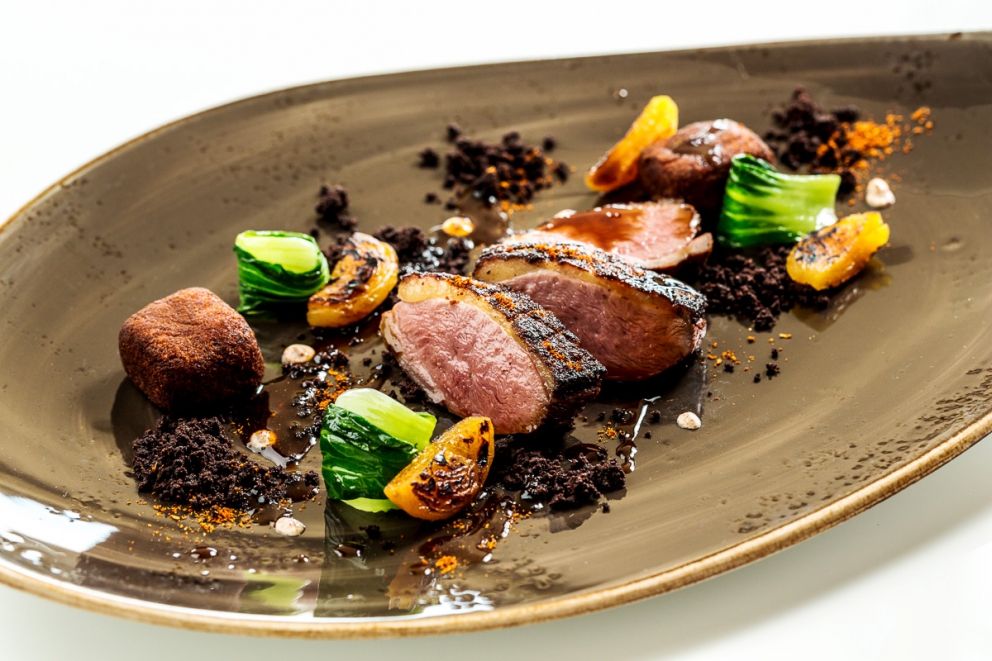 Photogallery






Iside De Cesare, La Parolina, Acquapendente (Viterbo)

Cod, garlic, oil and chilli pepper









Gianfranco Pascucci, Pascucci al Porticciolo, Fiumicino (Rome)

Eel tortelli in a broth of miso and caviar. Lake of Burano, WWF oasis: eel, myrtle and lentiscus. We’re collaborating with the WWF oases to give a "taste" to these places (photo by Andrea Di Lorenzo)









Claudio Petrolo, Claudio Petrolo, Gaeta (Latina)

Sea essence. Raw and cooked elements start an explosion with the flavour of the sea









Marco Bottega, Aminta resort, Genazzano (Rome)

Salmon, green apple and Orient spices. A meeting of sour, bitter, sweet and savoury









Rocco de Santis, Il Vistamare del Fogliano hotel, Latina

Red mullet in bread crust. A snack you can also eat with your hands, enclosing the scents of the South (I’m from Salerno): it’s like biting the sea together with onion, garlic, mint, lemon scents, raisins and pine nuts









Daniele Usai, Il Tino, Ostia (Rome)

Gnocchi with mandarin, with cod tripe and spinach. A historic dish from our menu has just returned in a current version









Gino Pesce, Acqua Pazza, Ponza (Latina)

Candele, cheese, pepper, white fish and courgettes. Created for a project we presented at Expo Milano with the goal of enhancing all the POD products of Lazio









Maurizio e Sandro Serva, La Trota, Rivodutri (Rieti)

Crayfish, roots, tubers, watercress with smoked trout and lake whitefish roe. A concentrate of flavours and lightness: roots, tubers and crayfish are steamed with aromatised water, with vegetable peels and Matcha tea. There’s no salt: the sapidity is giveb by the roe, the smokiness of the trout and the minerals in the vegetables and in the watercress, picked from our brook









Andrea Fusco, Giuda Ballerino, Rome

Venison sirloin with its jus and hibiscus, caramelised onions with blueberries and pistachio wafer. Serving a rich and lean red meat that is rarely served in this season









Cristina Bowerman, Glass Hostaria, Rome

Pasta and potatoes. Four different types of potatoes, with 4 different cooking methods, from mashed to crispy. Inspired by Bottura’s Compression of pasta and beans 









Anthony Genovese, Il Pagliaccio, Rome

Oyster, beetroot and coffee, snow of burrata. A journey across different scents, temperatures and textures






