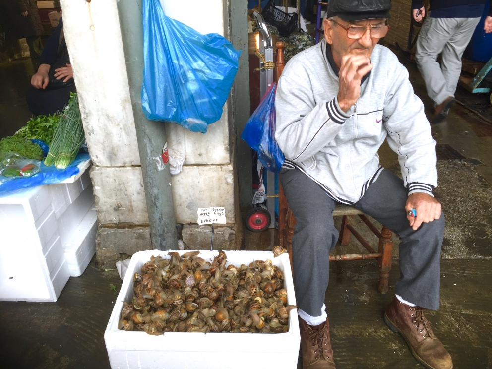 Photogallery






Breakfast with koulouri: you can find it all over town, we've chosen a kiosk between Korai and Stadiou, a stone's throw away from the university and not far from Psiri, the market area








Second stop, at Krinos (Aiolou 87): since 1922 it is the temple of loukoumades, pancakes fried in sesame oil and covered in honey and chopped almonds (loukuma is a word of Arab origins meaning nibble). A 6-piece portion costs 3.60 euros








The meat and fish market at Varvakios Agora (Athinas 42, a short walk from Krinos)








Come and grab some lamb!








Meat and fish market








Seafood delicacies. It's important to visit the fish market early in the morning because the best products are soon sold to restaurants













Walking around Psiri, Athens food corner








A pedlar selling salepi, an Ottoman drink made with dried orchid tubers





