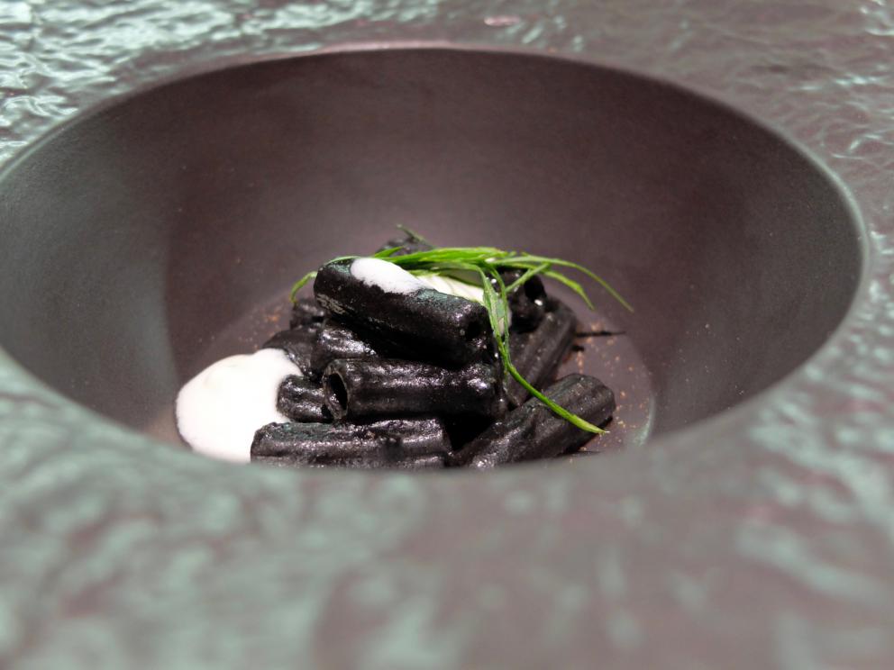 Photogallery






A new Lorenzo Cogo at the new El Coq, since July 2016 in the heart of Vicenza









At the entrance, the Carlton library by Ettore Sottsass, a great designer, founder of the  Memphis Group. In fact, it is entirely made in sugar, the work of artist Marco Chiurato

 









We get to the first floor: the perspective at the entrance recalls the depth of Palladio’s works









The elegant dining room









Precious cutlery by Giò Ponti for Sambonet. Everything is studied: the colour of the tablecloth is inspired by the roof of the Basilica Palladiana









The view from the dining room...









...and from the kitchen









Let’s start: Cherry tomato, angustura, vegetable jus. All the photos of the dishes are by Tanio Liotta









Beetroot macaroons with radicchio and Béarnaise sauce with mint 









Choux pastry with peanut cream and dried bacon 









Doughnut with goat cheese and curry cream: the last appetizer









Fondale marino, scalogno, salmone e salicornia: the shallot is chargrilled, there’s peppermint mousse, powdered salmon, and granita made with sea asparagus and orange bitter









Amberjack belly, rosola and peas: an improvisation based on what was available from the market. Fish and peas are chargrilled, then there’s a vinaigrette of pods and rosole, poppies









Chargrilled calamari, babaganush, bergamot and teriaki: the grill, once again. Cogo learnt its perfect use from Basque master Victor Arguinzoniz of Asador Etxebarri

 









Bosaga roe, yellow pepper, sake and ice camomile. Masterful what with complexity and elegance. Bosaga is a fish typical of Chioggia









Jerusalem artichoke "risotto", tuna bottarga and horseradish. There are many fake risottos available, such as the one with celeriac by Yoji Tokuyoshi and Salvatore Tassa or the vegetable one by Pedro Subijana. This is really perfect, with cream of Parmigiano and artichoke petals









Spaghetti with garlic and oil, hazelnut milk and seafood, with caviar of iced extra virgin olive oil and sea fennel. Beautiful, masterful and quite good too






