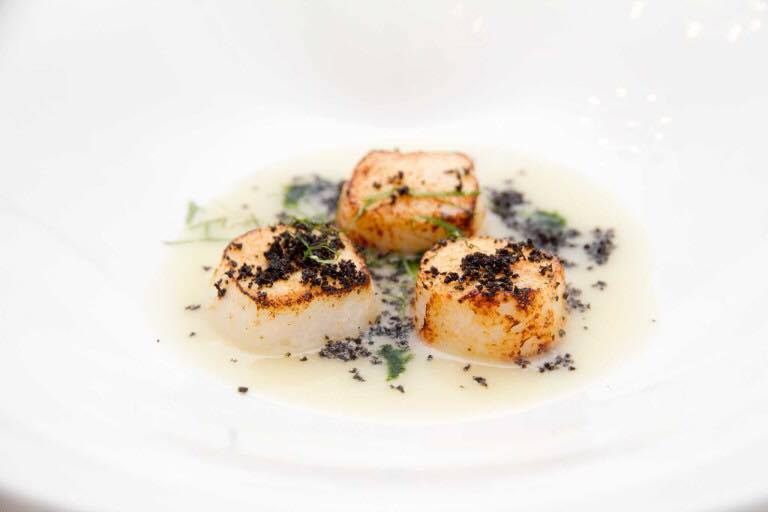 Photogallery






Iside De Cesare, La Parolina, Acquapendente (Viterbo)

Cod, garlic, oil and chilli pepper









Gianfranco Pascucci, Pascucci al Porticciolo, Fiumicino (Rome)

Eel tortelli in a broth of miso and caviar. Lake of Burano, WWF oasis: eel, myrtle and lentiscus. We’re collaborating with the WWF oases to give a "taste" to these places (photo by Andrea Di Lorenzo)









Claudio Petrolo, Claudio Petrolo, Gaeta (Latina)

Sea essence. Raw and cooked elements start an explosion with the flavour of the sea









Marco Bottega, Aminta resort, Genazzano (Rome)

Salmon, green apple and Orient spices. A meeting of sour, bitter, sweet and savoury









Rocco de Santis, Il Vistamare del Fogliano hotel, Latina

Red mullet in bread crust. A snack you can also eat with your hands, enclosing the scents of the South (I’m from Salerno): it’s like biting the sea together with onion, garlic, mint, lemon scents, raisins and pine nuts









Daniele Usai, Il Tino, Ostia (Rome)

Gnocchi with mandarin, with cod tripe and spinach. A historic dish from our menu has just returned in a current version









Gino Pesce, Acqua Pazza, Ponza (Latina)

Candele, cheese, pepper, white fish and courgettes. Created for a project we presented at Expo Milano with the goal of enhancing all the POD products of Lazio









Maurizio e Sandro Serva, La Trota, Rivodutri (Rieti)

Crayfish, roots, tubers, watercress with smoked trout and lake whitefish roe. A concentrate of flavours and lightness: roots, tubers and crayfish are steamed with aromatised water, with vegetable peels and Matcha tea. There’s no salt: the sapidity is giveb by the roe, the smokiness of the trout and the minerals in the vegetables and in the watercress, picked from our brook









Andrea Fusco, Giuda Ballerino, Rome

Venison sirloin with its jus and hibiscus, caramelised onions with blueberries and pistachio wafer. Serving a rich and lean red meat that is rarely served in this season









Cristina Bowerman, Glass Hostaria, Rome

Pasta and potatoes. Four different types of potatoes, with 4 different cooking methods, from mashed to crispy. Inspired by Bottura’s Compression of pasta and beans 









Anthony Genovese, Il Pagliaccio, Rome

Oyster, beetroot and coffee, snow of burrata. A journey across different scents, temperatures and textures









Francesco Apreda, Imàgo dell'hotel Hassler, Rome

Tandoori duck breast, cocoa earth and dried apricots. My personal take of a great classic from a continent I’m very fond of









Arcangelo Dandini, L'Arcangelo, Rome

My cipollata: zita with onion fondant with three spices. Taken from the Renaissance cipollata of Bartolomeo Scappi, the secret chef of 6 popes, who lived almost 30 years in Rome
 









Heinz Beck, La Pergola, Rome

S Campo. It’s the interpretation, with a modern take, of minestrone, made with lyophilisation. Each vegetable is cooked in the most suitable way so as to maintain its nutritional characteristics and then lyophilised. The result is 6, 7, 8 powders which are then put in the dish. The dish is served with scampi breaded with potatoes and soaked in front of the guest with a jus of this crustacean (photo by Janez Puksic)









Alba Esteve Ruiz, Marzapane, Rome

Chestnut cappeletti, raisins, smoked herring and seaweed infusion. Contrasts: the soft chestnut filling and a very persistent flavour, the smokiness and the fatness of the eel, the intense sweetness of the raisins, the sapidity of the seaweed infusion, the crispiness of the pasta...









Marco Baccanelli e Francesca Barreca, Mazzo, Rome

Roasted quails, baked tubers and roots, herb butter. The quails are served in their original shape, without deboning them. Our cuisine is moving towards a greater simplicity, and we can do so even by choosing classic yet not simple techniques









Roy Caceres, Metamorfosi, Roma

Mushrooms, flax brittle, black garlic and cream with Monviso blue cheese. In the seeming simplicity of an ingredient like mushrooms, contrasting textures give life to a dish in which their identity is surprisingly enhanced

 









Davide Del Duca, Osteria Fernanda, Rome

Snails, radish roots, Purgatorio beans, leaves and mustard seeds. A tribute to the material and primordial essence of the “earth” concept









Luciano Monosilio, Pipero al Rex, Rome

Vermicelli creamed in chicken broth, toasted spices and parmesan infusion. This recipe comes from spaghetti creamed in a very normal broth. The spices recall high mountains with the balsamic note counterbalanced by the sweet water of the parmesan. Almost like ramen









Marco Martini, Stazione di Posta, Rome

Steamed raviolo, chicken and broth of roasted potatoes. A meeting of east, west and my mother’s home









Francesco Sposito, Taverna Estia, Brusciano (Naples)

Tortellini with dandelion in a consommé of crustaceans. Introduced only recently, I’m very happy with it because it sums up the course we’ve taken









Vitantonio Lombardo, Locanda Severino, Caggiano (Salerno)

Mela Gras, that is to say mousse of chicken liver with dessert wine in a gelatine of annurca apples on a mixed leaf salad and hazelnuts from Giffoni. Creative and elegant cuisine with local products









Rosanna Marziale, Le Colonne, Caserta

Pasta with tomatoes. Paccheri from Gragnano with three types of tomatoes: San Marzano, piennolo and corbarino made with three different cooking techniques, with buffalo buttermilk









Pasquale Torrente, Al Convento, Cetara (Salerno)

'Ndunderi (ricotta gnocchi). These are pasta’s ancestors. They were born on the Amalfi Coast and are part of a project that this year, at Al Convento, will rediscover ancient local recipes









Christoph Bob, Monastero di Santa Rosa, Conca dei Marini (Salerno)

Linguine with nettle emulsion, salicornia and sea truffles









Giulio Coppola, La Galleria, Gragnano (Naples)

Spaghetti with lemon, with beef muzzle, pesto of olives, lupines and rocket salad. It says a lot about my territory and recalls the O Per e Muss, a street food recipe that people enjoy in the evenings in the South all year round









Pasquale Palamaro, Indaco del Regina Isabella, Ischia (Naples)

Sea foie gras. Cod liver prepared like the French geese one to make foie gras. Paired with cabbage, beetroot, ginger and toasted bread









Alfonso Caputo, La Taverna del Capitano, Massa Lubrense (Naples)

Seabream and prawns, figs and moka with sea urchin needles. The richness of the sea with the addition of an iodine note to enhance the taste through all the senses (in the photo, the summer version with cherry tomatoes from Vesuvius)









Salvatore Bianco, Il Comandante at Romeo hotel, Naples

Squid and bamboo with emulsion of cardamom with citrus fruits, soft potato with soy milk and black olives. It fully represents my cooking philosophy: ingredients from my homeland meet raw materials from different cultures
 









Lino Scarallo, Palazzo Petrucci, Naples

Soused red mullet with a soy reduction, couscous of Roman cabbage, papaccelle and black olives. Together with the red mullet, this recipe is based on raw materials from our traditional cuisine, with a modern take, an international interpretation inspired by the Japanese preparation of eels
 









Gianluca D'Agostino, Veritas, Naples

Roasted mackerel with fresella, tomato and goat cheese. It’s my take on fresella with tomato and tuna/anchovies









Marianna Vitale, Sud, Quarto (Naples)

Spaghettoni with artichokes, sea urchins and cinnamon. Sweet, bitter and spicy notes are matched with the aftertaste of the sea rust (as of February it will be part of a whole menu only made of pasta)









Michele Deleo, Rossellinis di Palazzo Avino, Ravello (Salerno)

Variations on pasta, cornaioli peas, gobbo prawn and sea roe. This dish was inspired by Pasta and peas, an old recipe typical of Campania, which included the use of a beaten egg to thicken everything. I used sea roe (bottarga, sea urchns and prawns) instead of bird eggs and I didn’t cook the pasta with the peas but in a seafood broth. I finally mixed everything with sweet pecorino and crushed pepper









Lorenzo Cuomo, Re Maurì at Lloyd's Baia hotel, Salerno

Spaghetti alla chitarra with oil aromatised with oranges, turnip tops, crispy calamari and sea urchins. A rhythmical pinwheel of flavours and textures









Ernesto Iaccarino, Don Alfonso, Sant'Agata sui Due Golfi (Naples)

Crispy crustacean cylinder and emulsion of its roe with soft buffalo milk mozzarella and organic vegetables from the kitchen garden in Punta Campanella. An unusual pairing of buffalo milk mozzarella and shellfish, based on the affinity between the sweet and savoury notes of both









Giovanni Sorrentino, Gerani, Santa Maria La Carità (Naples)

Tagliolino with raw and cooked white prawns, buffalo milk yogurt, baked cherry tomatoes and liquorice. It perfectly sums up my passion and my approach in cooking. My homeland looked at with the eyes of someone who’s back after a long journey






