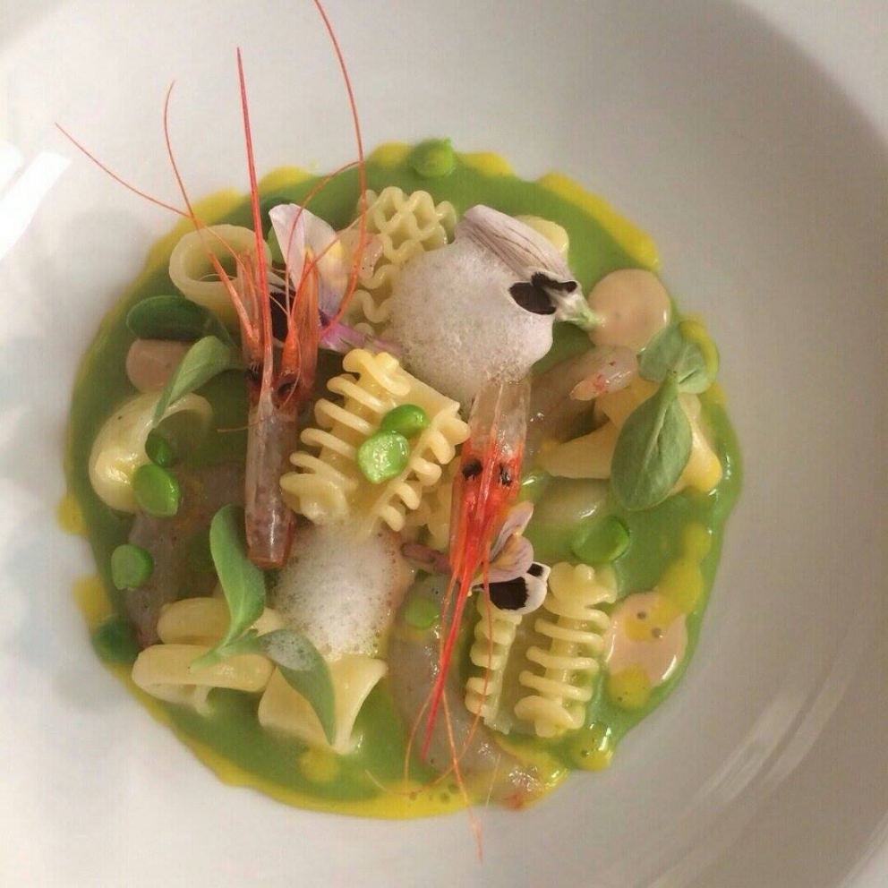 Photogallery






Iside De Cesare, La Parolina, Acquapendente (Viterbo)

Cod, garlic, oil and chilli pepper









Gianfranco Pascucci, Pascucci al Porticciolo, Fiumicino (Rome)

Eel tortelli in a broth of miso and caviar. Lake of Burano, WWF oasis: eel, myrtle and lentiscus. We’re collaborating with the WWF oases to give a "taste" to these places (photo by Andrea Di Lorenzo)









Claudio Petrolo, Claudio Petrolo, Gaeta (Latina)

Sea essence. Raw and cooked elements start an explosion with the flavour of the sea









Marco Bottega, Aminta resort, Genazzano (Rome)

Salmon, green apple and Orient spices. A meeting of sour, bitter, sweet and savoury









Rocco de Santis, Il Vistamare del Fogliano hotel, Latina

Red mullet in bread crust. A snack you can also eat with your hands, enclosing the scents of the South (I’m from Salerno): it’s like biting the sea together with onion, garlic, mint, lemon scents, raisins and pine nuts









Daniele Usai, Il Tino, Ostia (Rome)

Gnocchi with mandarin, with cod tripe and spinach. A historic dish from our menu has just returned in a current version









Gino Pesce, Acqua Pazza, Ponza (Latina)

Candele, cheese, pepper, white fish and courgettes. Created for a project we presented at Expo Milano with the goal of enhancing all the POD products of Lazio









Maurizio e Sandro Serva, La Trota, Rivodutri (Rieti)

Crayfish, roots, tubers, watercress with smoked trout and lake whitefish roe. A concentrate of flavours and lightness: roots, tubers and crayfish are steamed with aromatised water, with vegetable peels and Matcha tea. There’s no salt: the sapidity is giveb by the roe, the smokiness of the trout and the minerals in the vegetables and in the watercress, picked from our brook









Andrea Fusco, Giuda Ballerino, Rome

Venison sirloin with its jus and hibiscus, caramelised onions with blueberries and pistachio wafer. Serving a rich and lean red meat that is rarely served in this season









Cristina Bowerman, Glass Hostaria, Rome

Pasta and potatoes. Four different types of potatoes, with 4 different cooking methods, from mashed to crispy. Inspired by Bottura’s Compression of pasta and beans 









Anthony Genovese, Il Pagliaccio, Rome

Oyster, beetroot and coffee, snow of burrata. A journey across different scents, temperatures and textures









Francesco Apreda, Imàgo dell'hotel Hassler, Rome

Tandoori duck breast, cocoa earth and dried apricots. My personal take of a great classic from a continent I’m very fond of









Arcangelo Dandini, L'Arcangelo, Rome

My cipollata: zita with onion fondant with three spices. Taken from the Renaissance cipollata of Bartolomeo Scappi, the secret chef of 6 popes, who lived almost 30 years in Rome
 









Heinz Beck, La Pergola, Rome

S Campo. It’s the interpretation, with a modern take, of minestrone, made with lyophilisation. Each vegetable is cooked in the most suitable way so as to maintain its nutritional characteristics and then lyophilised. The result is 6, 7, 8 powders which are then put in the dish. The dish is served with scampi breaded with potatoes and soaked in front of the guest with a jus of this crustacean (photo by Janez Puksic)









Alba Esteve Ruiz, Marzapane, Rome

Chestnut cappeletti, raisins, smoked herring and seaweed infusion. Contrasts: the soft chestnut filling and a very persistent flavour, the smokiness and the fatness of the eel, the intense sweetness of the raisins, the sapidity of the seaweed infusion, the crispiness of the pasta...









Marco Baccanelli e Francesca Barreca, Mazzo, Rome

Roasted quails, baked tubers and roots, herb butter. The quails are served in their original shape, without deboning them. Our cuisine is moving towards a greater simplicity, and we can do so even by choosing classic yet not simple techniques









Roy Caceres, Metamorfosi, Roma

Mushrooms, flax brittle, black garlic and cream with Monviso blue cheese. In the seeming simplicity of an ingredient like mushrooms, contrasting textures give life to a dish in which their identity is surprisingly enhanced

 









Davide Del Duca, Osteria Fernanda, Rome

Snails, radish roots, Purgatorio beans, leaves and mustard seeds. A tribute to the material and primordial essence of the “earth” concept









Luciano Monosilio, Pipero al Rex, Rome

Vermicelli creamed in chicken broth, toasted spices and parmesan infusion. This recipe comes from spaghetti creamed in a very normal broth. The spices recall high mountains with the balsamic note counterbalanced by the sweet water of the parmesan. Almost like ramen









Marco Martini, Stazione di Posta, Rome

Steamed raviolo, chicken and broth of roasted potatoes. A meeting of east, west and my mother’s home









Francesco Sposito, Taverna Estia, Brusciano (Naples)

Tortellini with dandelion in a consommé of crustaceans. Introduced only recently, I’m very happy with it because it sums up the course we’ve taken









Vitantonio Lombardo, Locanda Severino, Caggiano (Salerno)

Mela Gras, that is to say mousse of chicken liver with dessert wine in a gelatine of annurca apples on a mixed leaf salad and hazelnuts from Giffoni. Creative and elegant cuisine with local products









Rosanna Marziale, Le Colonne, Caserta

Pasta with tomatoes. Paccheri from Gragnano with three types of tomatoes: San Marzano, piennolo and corbarino made with three different cooking techniques, with buffalo buttermilk









Pasquale Torrente, Al Convento, Cetara (Salerno)

'Ndunderi (ricotta gnocchi). These are pasta’s ancestors. They were born on the Amalfi Coast and are part of a project that this year, at Al Convento, will rediscover ancient local recipes









Christoph Bob, Monastero di Santa Rosa, Conca dei Marini (Salerno)

Linguine with nettle emulsion, salicornia and sea truffles









Giulio Coppola, La Galleria, Gragnano (Naples)

Spaghetti with lemon, with beef muzzle, pesto of olives, lupines and rocket salad. It says a lot about my territory and recalls the O Per e Muss, a street food recipe that people enjoy in the evenings in the South all year round









Pasquale Palamaro, Indaco del Regina Isabella, Ischia (Naples)

Sea foie gras. Cod liver prepared like the French geese one to make foie gras. Paired with cabbage, beetroot, ginger and toasted bread









Alfonso Caputo, La Taverna del Capitano, Massa Lubrense (Naples)

Seabream and prawns, figs and moka with sea urchin needles. The richness of the sea with the addition of an iodine note to enhance the taste through all the senses (in the photo, the summer version with cherry tomatoes from Vesuvius)









Salvatore Bianco, Il Comandante at Romeo hotel, Naples

Squid and bamboo with emulsion of cardamom with citrus fruits, soft potato with soy milk and black olives. It fully represents my cooking philosophy: ingredients from my homeland meet raw materials from different cultures
 









Lino Scarallo, Palazzo Petrucci, Naples

Soused red mullet with a soy reduction, couscous of Roman cabbage, papaccelle and black olives. Together with the red mullet, this recipe is based on raw materials from our traditional cuisine, with a modern take, an international interpretation inspired by the Japanese preparation of eels
 









Gianluca D'Agostino, Veritas, Naples

Roasted mackerel with fresella, tomato and goat cheese. It’s my take on fresella with tomato and tuna/anchovies









Marianna Vitale, Sud, Quarto (Naples)

Spaghettoni with artichokes, sea urchins and cinnamon. Sweet, bitter and spicy notes are matched with the aftertaste of the sea rust (as of February it will be part of a whole menu only made of pasta)






