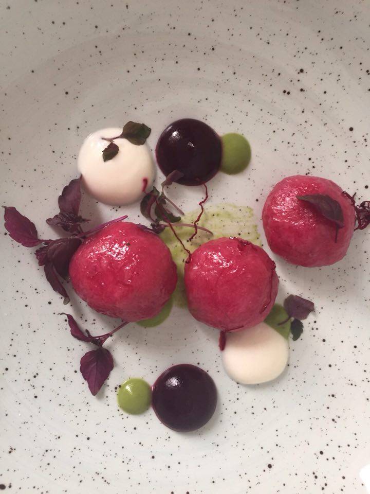 Photogallery






Gianni Dezio, Tosto, Atri (Teramo)

Tortelli with artichokes, fondue of pecorino from Atri, mint and liquorice. Liquorice and mint unite so as to enhance one of the most important vegetables in Italian cuisine









Valerio Centofanti, L'Angolo d'Abruzzo, Carsoli (L'Aquila)

Pappardelle with gelded lamb with pecorino from Alta Valle del Turano. The lamb is gelded before it is two months’ old and raised for 18 months. A dish full of emotions and sensations that has disappeared from Italian kitchens (in the picture, the gelded lamb)









Niko Romito, Reale Casadonna, Castel di Sangro (L'Aquila)

Because it’s the proof that constant research in the kitchen (in this case applied to cutting and macerating cabbage) can pull down the "wall" of vegetal representation and give new and powerful solutions in terms of structure and taste. Creating surprise and deep emotion. For me, it represents a new phase









Mattia Spadone, La Bandiera, Civitella Casanova (Pescara)

Vegetables cooked in salt. I worked on cooking in salt only using vegetables (from our kitchen garden). It may seem banal but I’ve been working on this for over 3 months: these are roots and leaves presented in different textures, crispy, mashed and thinly diced









Patrizia Corradetti, Zenobi, Colonnella (Teramo)

Meat and spinach ravioli with Neapolitan genovese sauce. I needed to include in the mid-August menu a first course with filled pasta that would still be traditional









Nadia Moscardi, Elodia nel Parco, L'Aquila

Textures of pasta and vegetable garden. It is inspired by Le Virtù, an ancient soup from Abruzzo that was made by the bride for the future mother-in-law to prove her virtues in the kitchen










William Zonfa, Magione Papale, L'Aquila

Castratissimo. Gelded meat is very popular in Abruzzo. The sauce you see is a dehydrated “veil of gelded meat sauce”, wrapping the soft meat. Upon contact with the heat and humidity of the meat, it is rehydrated and gives life to the memory of meat chops coming out from the sauce itself









Cinzia Mancini, Bottega Culinaria Biologica, San Vito Chietino (Chieti)

Pescatrice noir. My territory and the elements defining it: sun, rocks, sea, wind and fire









Stefania Di Pasquo, Locanda Mammì, Agnone (Isernia)

Raspberry mousse with caramelised white chocolate and hazelnuts. It’s a non-sweet sweet, a dessert that represents a change from the classic desserts I have in the menu. It represents my current desire for change









Felice Sgarra, Umami, Andria

Cream of cannellini beans and scampi with lemon sourness. A fresh course but also one that is suitable for every occasion
 









Antonio Scalera, La Bul, Bari

Home-smoked mackerel, toasted walnuts, jam and gelatine of friggitelli peppers. Blue tailed fish: poor, from the tradition and history of Apulia. Cinderella becomes the queen on our table









Giovanni Lorusso, Memory resort, Bisceglie (Barletta, Andria e Trani)

Sea bass, smoked Jerusalem artichoke, green affilla and sesame praliné. The fish, the aroma of almonds, the sauce of smoked Jerusalem artichoke, the aroma of the baby peas that have just sprouted and the sesame praliné adding sweetness and balsamic notes






