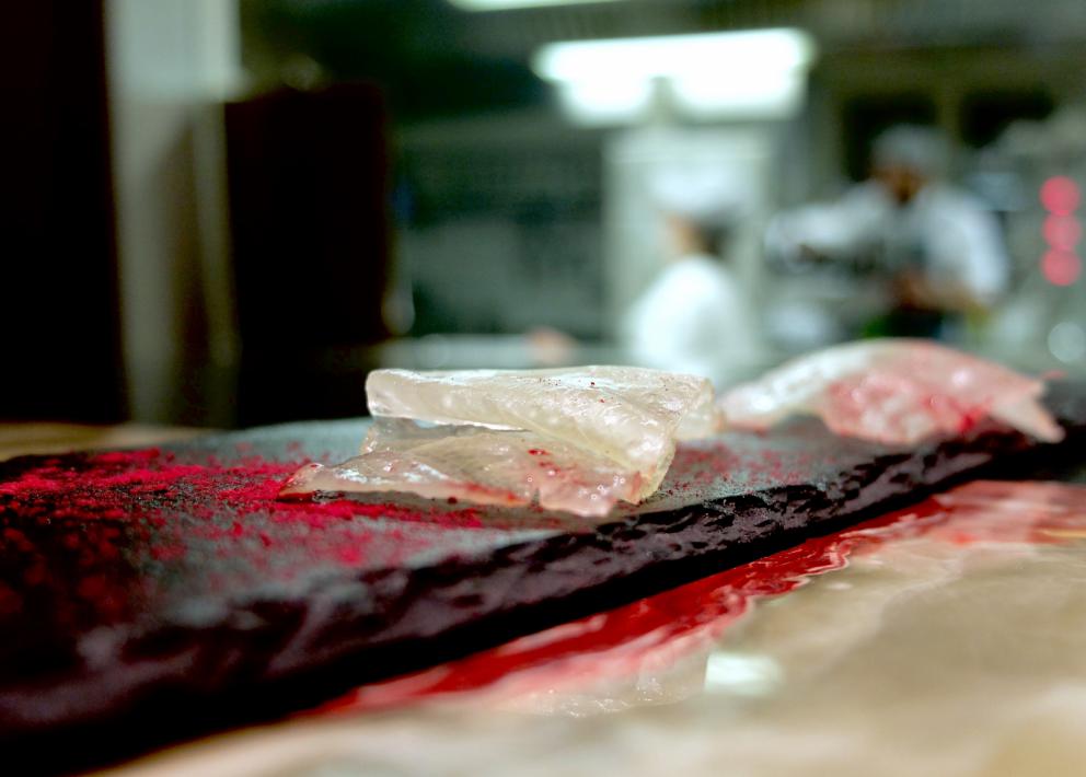 Photogallery






A new Lorenzo Cogo at the new El Coq, since July 2016 in the heart of Vicenza









At the entrance, the Carlton library by Ettore Sottsass, a great designer, founder of the  Memphis Group. In fact, it is entirely made in sugar, the work of artist Marco Chiurato

 









We get to the first floor: the perspective at the entrance recalls the depth of Palladio’s works









The elegant dining room









Precious cutlery by Giò Ponti for Sambonet. Everything is studied: the colour of the tablecloth is inspired by the roof of the Basilica Palladiana









The view from the dining room...









...and from the kitchen









Let’s start: Cherry tomato, angustura, vegetable jus. All the photos of the dishes are by Tanio Liotta









Beetroot macaroons with radicchio and Béarnaise sauce with mint 









Choux pastry with peanut cream and dried bacon 









Doughnut with goat cheese and curry cream: the last appetizer









Fondale marino, scalogno, salmone e salicornia: the shallot is chargrilled, there’s peppermint mousse, powdered salmon, and granita made with sea asparagus and orange bitter









Amberjack belly, rosola and peas: an improvisation based on what was available from the market. Fish and peas are chargrilled, then there’s a vinaigrette of pods and rosole, poppies









Chargrilled calamari, babaganush, bergamot and teriaki: the grill, once again. Cogo learnt its perfect use from Basque master Victor Arguinzoniz of Asador Etxebarri

 









Bosaga roe, yellow pepper, sake and ice camomile. Masterful what with complexity and elegance. Bosaga is a fish typical of Chioggia









Jerusalem artichoke "risotto", tuna bottarga and horseradish. There are many fake risottos available, such as the one with celeriac by Yoji Tokuyoshi and Salvatore Tassa or the vegetable one by Pedro Subijana. This is really perfect, with cream of Parmigiano and artichoke petals









Spaghetti with garlic and oil, hazelnut milk and seafood, with caviar of iced extra virgin olive oil and sea fennel. Beautiful, masterful and quite good too









Gargato, squid liver, mousse of buffalo milk mozzarella and ginseng. Gargato is a small maccherone. A delicious dish






