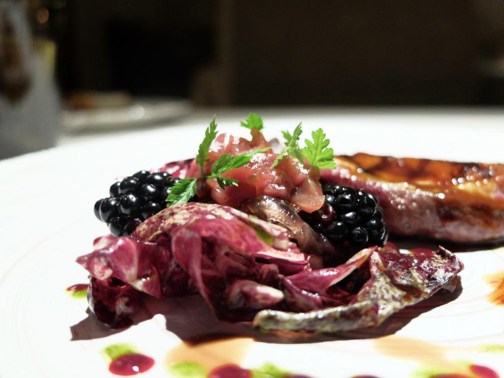 PhotogalleryOur dinner at Stube Gourmet, depicted by Tanio Liotta. We start with Duck breast, pumpkin mostarda, sesame wafer and tarragon 
Savoury cone with veal steak tartare, marjoram and salmon roe
A reconstructed tomato: mousse of tomato, vegetal carbon, mousse of almonds, basil gel
Fake peanut with foie gras, cocoa butter, horn of plenty 
Excellent bread and butter
Giardino di verdure, terra di mandorla, formaggio caprino: marinated, dehydrated, raw or cooked vegetables, with powdered beetroots, almonds and goat cheese
Codfish pearls, dashi broth, ginger, coriander. These gnocchetti look like they&rsquo;re made with potatoes but it&rsquo;s cod and flour
Spaghetti with spinach chlorophyll, daikon, mozzarella, herring roe. The mozzarella is in fact mozzarella water, daikon is in the shape of gel, plus nasturtium sprouts
Carnaroli rice, tarragon, cucumber, currants
Duck foie gras escalope, orange pan brioche, granny smith gel, candied watermelon
Pigeon in three styles of cooking. In this case leg confit with blackberries and hazelnut sauce
