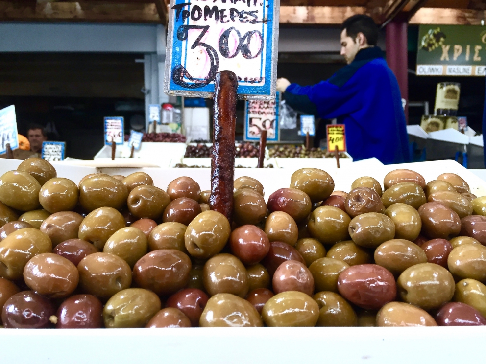 Photogallery






Breakfast with koulouri: you can find it all over town, we've chosen a kiosk between Korai and Stadiou, a stone's throw away from the university and not far from Psiri, the market area








Second stop, at Krinos (Aiolou 87): since 1922 it is the temple of loukoumades, pancakes fried in sesame oil and covered in honey and chopped almonds (loukuma is a word of Arab origins meaning nibble). A 6-piece portion costs 3.60 euros








The meat and fish market at Varvakios Agora (Athinas 42, a short walk from Krinos)








Come and grab some lamb!








Meat and fish market








Seafood delicacies. It's important to visit the fish market early in the morning because the best products are soon sold to restaurants













Walking around Psiri, Athens food corner








A pedlar selling salepi, an Ottoman drink made with dried orchid tubers








Slow food








Halva, a popular cake from India to the East of the Mediterranean Sea, based on tahina, a sesame paste. The word halva comes from the ancient Jewish where it meant 