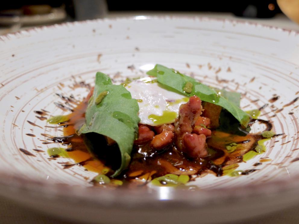 PhotogalleryOur dinner at Stube Gourmet, depicted by Tanio Liotta. We start with Duck breast, pumpkin mostarda, sesame wafer and tarragon 
Savoury cone with veal steak tartare, marjoram and salmon roe
A reconstructed tomato: mousse of tomato, vegetal carbon, mousse of almonds, basil gel
Fake peanut with foie gras, cocoa butter, horn of plenty 
Excellent bread and butter
Giardino di verdure, terra di mandorla, formaggio caprino: marinated, dehydrated, raw or cooked vegetables, with powdered beetroots, almonds and goat cheese
Codfish pearls, dashi broth, ginger, coriander. These gnocchetti look like they&rsquo;re made with potatoes but it&rsquo;s cod and flour
Spaghetti with spinach chlorophyll, daikon, mozzarella, herring roe. The mozzarella is in fact mozzarella water, daikon is in the shape of gel, plus nasturtium sprouts
Carnaroli rice, tarragon, cucumber, currants
Duck foie gras escalope, orange pan brioche, granny smith gel, candied watermelon
Pigeon in three styles of cooking. In this case leg confit with blackberries and hazelnut sauce
Pigeon tartare on radicchio, compote of onions and blackberries
Chargrilled pigeon breast
