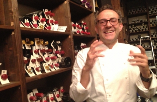 Photogallery






 
Modena’s colonnades, 186 thousand inhabitants and 3 restaurants with at least one Michelin star: Hostaria del Mare (1), Erba del Re (1) and Osteria Francescana (3 stars), our destination
 








Yellow and red tones prevail








The city still bears the signs of the May 2012 earthquake. On May 4th 2013, the day of our visit, a 3.8 magnitude earthquake was registered













By chance, Giuseppe Palmieri, maître and sommelier, appears from the grey door








Palmieri, 38, born in Matera. His first service in Francescana was on September 12th 2000








The old entrance to the restaurant, at number 24 in Via della Stella - as on the opening in 1995. It changed in September 2012: today you enter from number 22. Funnily enough, Google Maps is still set on the old entrance








The present entrance doors








Let’s start








After the latest renovations, the transit areas inside the Osteria appear as a contemporary art gallery








Mario Schifano’s world map








"Tourists", Maurizio Cattelan’s famous pigeons








Underneath the pigeons, Gavin Turk’s “Trashbag”








Three rooms, 12 tables, between 20 to 35 guests. 40% guests are Italian








Every table is illuminated by Davide Groppi’s Sampei lamp: if tables are moved, light follows








Francescana receives 150 reservations every day. But it also suffers from clients not showing up: on average, one table every week is booked but then guests don’t come








Right behind the kitchen, there’s the prêt-à-porter cellar








"In the central cellar, we only keep great vintages and larger bottles of what we consider to be great wines", Beppe Palmieri explains








1,600 wines are listed at Osteria Francescana, with a deep wine list which includes different vintages of the same wine








"A true celebration of wine "








The Ferrari coat, hanging in the cellar: Maranello is only 17 km away from Modena








Jean Todt, Michael Schumacher, Fernando Alonso: Ferrari’s “prancing horse” is at home in Via Stella








Gabrio Bini’s wines, from Pantelleria, a real fetish for Palmieri













Hanging from the ceiling, a nice selection of cured meats from Emilia








Bread made with mother yeast, the premise to a journey which will alternate great classics with very contemporary dishes








Massimo Bottura. Fifty years old last September, he is chef since 1986, the year of Trattoria del Campazzo in Nonantola. His first masters: Lidia Cristoni and Georges Cogny





