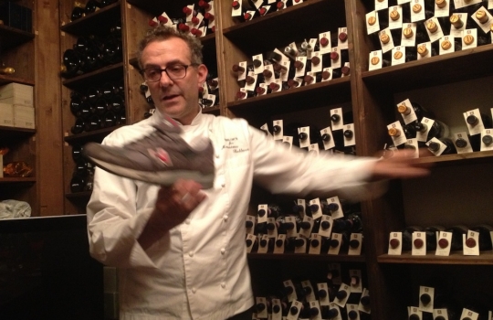 Photogallery






 
Modena’s colonnades, 186 thousand inhabitants and 3 restaurants with at least one Michelin star: Hostaria del Mare (1), Erba del Re (1) and Osteria Francescana (3 stars), our destination
 








Yellow and red tones prevail








The city still bears the signs of the May 2012 earthquake. On May 4th 2013, the day of our visit, a 3.8 magnitude earthquake was registered













By chance, Giuseppe Palmieri, maître and sommelier, appears from the grey door








Palmieri, 38, born in Matera. His first service in Francescana was on September 12th 2000








The old entrance to the restaurant, at number 24 in Via della Stella - as on the opening in 1995. It changed in September 2012: today you enter from number 22. Funnily enough, Google Maps is still set on the old entrance








The present entrance doors








Let’s start








After the latest renovations, the transit areas inside the Osteria appear as a contemporary art gallery








Mario Schifano’s world map








"Tourists", Maurizio Cattelan’s famous pigeons








Underneath the pigeons, Gavin Turk’s “Trashbag”








Three rooms, 12 tables, between 20 to 35 guests. 40% guests are Italian








Every table is illuminated by Davide Groppi’s Sampei lamp: if tables are moved, light follows








Francescana receives 150 reservations every day. But it also suffers from clients not showing up: on average, one table every week is booked but then guests don’t come








Right behind the kitchen, there’s the prêt-à-porter cellar








"In the central cellar, we only keep great vintages and larger bottles of what we consider to be great wines", Beppe Palmieri explains








1,600 wines are listed at Osteria Francescana, with a deep wine list which includes different vintages of the same wine








"A true celebration of wine "








The Ferrari coat, hanging in the cellar: Maranello is only 17 km away from Modena








Jean Todt, Michael Schumacher, Fernando Alonso: Ferrari’s “prancing horse” is at home in Via Stella








Gabrio Bini’s wines, from Pantelleria, a real fetish for Palmieri













Hanging from the ceiling, a nice selection of cured meats from Emilia








Bread made with mother yeast, the premise to a journey which will alternate great classics with very contemporary dishes








Massimo Bottura. Fifty years old last September, he is chef since 1986, the year of Trattoria del Campazzo in Nonantola. His first masters: Lidia Cristoni and Georges Cogny








He’s glowing: a few days ago his restaurant climbed, for the first time, onto the podium of the World's 50Best, a prize that is acquiring an increasing weight and authority. "The thing that makes me the happiest", he says, "is not so much the third place, but the fact that we’ve been in the highest positions for a few years now". True: 13th in 2009, 6th in 2010, 4th in 2011, 5th in 2012, 3rd in 2013





