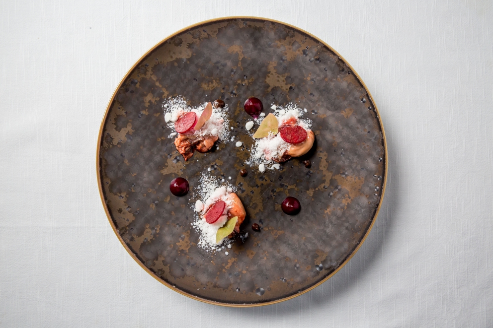 Photogallery






Iside De Cesare, La Parolina, Acquapendente (Viterbo)

Cod, garlic, oil and chilli pepper









Gianfranco Pascucci, Pascucci al Porticciolo, Fiumicino (Rome)

Eel tortelli in a broth of miso and caviar. Lake of Burano, WWF oasis: eel, myrtle and lentiscus. We’re collaborating with the WWF oases to give a "taste" to these places (photo by Andrea Di Lorenzo)









Claudio Petrolo, Claudio Petrolo, Gaeta (Latina)

Sea essence. Raw and cooked elements start an explosion with the flavour of the sea









Marco Bottega, Aminta resort, Genazzano (Rome)

Salmon, green apple and Orient spices. A meeting of sour, bitter, sweet and savoury









Rocco de Santis, Il Vistamare del Fogliano hotel, Latina

Red mullet in bread crust. A snack you can also eat with your hands, enclosing the scents of the South (I’m from Salerno): it’s like biting the sea together with onion, garlic, mint, lemon scents, raisins and pine nuts









Daniele Usai, Il Tino, Ostia (Rome)

Gnocchi with mandarin, with cod tripe and spinach. A historic dish from our menu has just returned in a current version









Gino Pesce, Acqua Pazza, Ponza (Latina)

Candele, cheese, pepper, white fish and courgettes. Created for a project we presented at Expo Milano with the goal of enhancing all the POD products of Lazio









Maurizio e Sandro Serva, La Trota, Rivodutri (Rieti)

Crayfish, roots, tubers, watercress with smoked trout and lake whitefish roe. A concentrate of flavours and lightness: roots, tubers and crayfish are steamed with aromatised water, with vegetable peels and Matcha tea. There’s no salt: the sapidity is giveb by the roe, the smokiness of the trout and the minerals in the vegetables and in the watercress, picked from our brook









Andrea Fusco, Giuda Ballerino, Rome

Venison sirloin with its jus and hibiscus, caramelised onions with blueberries and pistachio wafer. Serving a rich and lean red meat that is rarely served in this season









Cristina Bowerman, Glass Hostaria, Rome

Pasta and potatoes. Four different types of potatoes, with 4 different cooking methods, from mashed to crispy. Inspired by Bottura’s Compression of pasta and beans 






