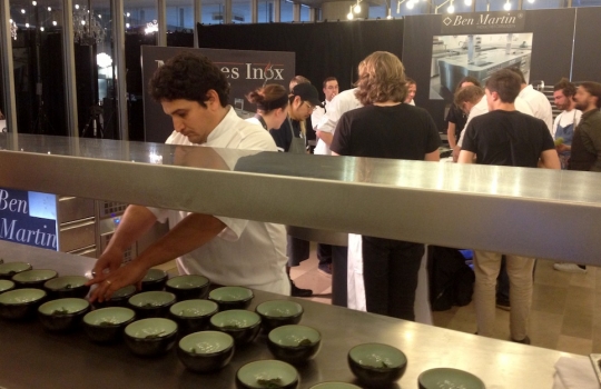 Photogallery






With 250thousand inhabitants, Gent (or Gand) is the third largest city in Belgium. With its canals and its laid back life, it competes with Bruges for the title most beautiful city in the Flanders 








The Sunday began at the Flemish Food Fest, a festival in which everyone was grilling all sorts of food. In the photo, the chef table with many of the chefs that were to be the protagonists of the Gelinaz! dinner








Colagreco, Redzepi and the kitchen-van. The location was kept secret until the beginning of the show, at around 7 pm








The two long tables set at the Icc in Gent. Three shifts: 1-8, 9-16, 17-24. We were so lucky we enjoyed them all








In the kitchen, works to dismember the chickens from Gent begin








"Even I don’t know what will happen tonight. And please remember: this is a performance, not a dinner", says Andrea Petrini, founder and curator of the event named after chef Fulvio Pieran-gelinaz and by Gorillaz, the temporary band that Blur’s Damon Albarn creates whenever he feels like it. The black sculpture underneath the Madonna is that of    Philippe Édouard Cauderlier (Antwerp, 1812-1887)








It all starts by quoting Kubrick and Eyes Wide Shot... Each dish is a song. And each of the three acts is separated by various artistic performances. In the dining room, men act as nothing is going on in front of their partners








First dish of the Gelinaz evening, Philippe Edouard Cauderlier’s Cold-hot chicken timbale, the original recipe from     1861. Roger Souvereyns of Scholteshof in Stevoort had the honour of performing it at the Icc in Gent








Inaki Aizpitarte     ’s Royal chicken kir, using all the ingredients in the original recipe. The wine is diluted in the chicken stock. The dish arrives together with     Wu Tang Clan’s rap








Anataoly Komm of Varvary in Moscow, lets us taste his Maki Roll behind the scenes








Komm’s Maki roll: chicken and vegetables wrapped in a turnip leaf. The sauce is made with walnuts, a Caucasian tradition








Agata Felluga ’s Lotus timbale. She’s the Italian sous chef at Chateaubriand in Paris, with a previous experience at Pascal Barbot’sAstrance. The dish is inspired by a Japanese sticky rice recipe, where the rice is cooked in a lotus leaf. Here, instead, there’s    Cauderlier’s chicken, together with miso, tamarind syrup, pork fat, soy sauce. A very complex dish.








Left, 32 year old Agata Felluga, born in Rome and adopted by the Ville Lumiére








Petter Nilsson’s Bread chicken, from the Gazzetta in Paris. It is made with all the cereals hens eat during their life: corn, hulled wheat, barley, rye and wheat. The photo of the bag is a portrait of the Danish chef’s creation








Massimo Bottura     is not in Gent, however, in a coup de theatre, his brother Paolo takes his place, here on the left with Alberto Buratti,     pastry-chef at Osteria Francescana. The chef from Modena explains in a video the reason behind his absence: "In Modena, his team is so finely     tuned that even my car-salesman brother can take my place", he jokes








Even in Bottura’s dish there’s no traditional chicken: it’s called Chicken, chicken, where are you? It is the re-interpretation     of the classic chicken salad, with a stock made with roasted chicken below, and a cotechino (cooked pork sausage) and agar-agar gelatine with very small dices of peas, carrots, potatoes, red and yellow peppers, onions, tomatoes... in the background, "What about the noise?" by    John Cage strikes us








Pea tendrils with chicken and mint aspic     by Blaine Wetzel, once a pupil of Redzepi, today back home in Lummi Island, a paradise in the middle of nowhere, in     Washington state. The tendrils are grilled. A great dish, with a super balance between smoke, balsamic and acid notes








Chia and chicken with tiger milk, turnips and coca leaves , that is to say "The chicken of Gent meets South America", a journey of the mind, from the Pacific ocean to the Andes to the Amazon forest led by Peruvian    Virgilio Martinez








Virgilio Martinez     at work with Alberto Buratti








Chicken liver, scallion with tarragon, turnip and toasted cauliflower stock by Basque Josean Alija








French-Spanish journalist Maria Canabal and Josean Martinez Alija








Poulet-mayo by Bertrand Grébaut of   Septime in Paris, a cold entrée with all the ingredients of the original recipe. In the background, Rufus Thomas ’s r 'n' b with "Do the funky chicken"








Reneè Redzepi has no doubt when it comes to which is the best part of the chicken: the skin. Half of the guest, as it turned out, agreed with him








Redzepi, on the left, explains his passion for chicken, discovered when he was a child in Macedonia. "I had to prepare this dish at home because it is fucking complicated"








Here it is: it’s not exactly chicken skin, but the “skin” made with a stock prepared using all the ingredients in Cauderlier’s recipe, removing the froth. A single, fantastic morsel, one of the many intervals that compose the first part of a dinner at Noma








We peek into the iPad of Italian Emilia Terragni who works for Phaidon in London, and is sitting at the table next to     ours, and we see a juicy preview: the triple format of Renè Redzepi’s next book, which will be out in November. It’s a sort of diary, an     intimate one, too, in which he explains how difficult dealing with the limelight is








The monumental “skyscrapers” of Six degrees of separations, Davide Scabin’s fantastic idea








In Scabin’s dish, there are 6 of the ingredients in the original recipe, but cooked separately, 6 "morsels" composed by: 1. Porto gelatine with carrot, pea and pea gelatine 2. Chicken mousse filled with livers and two pop corns to keep them firm 3. A pork jelly with tarragon vinegar 4. Cucumber roll with French beans and soy sauce jelly 5. Pork feet and tongue gelatine. And the 6th? Sorry, no response. On the left we find a light chicken royale served in a Martini glass








The Combal.Zero Trio, from Rivoli. In the background, the chosen music was Frank Zappa’s dystonic Bolero








Not a chicken     , in fact it is an oyster with a spicy tabbouleh with pork feet. An extraordinary dish by Daniel Patterson of Coi in San     Francisco. In the background, "Cool Thing", progressive rock by Sonic Youth








Chicken tea by Eneko Atxa. Cooked in infusion in the coffee machine, it includes chicken cut into pieces, carrots, onions, cauliflowers, French beans, baby carrots and edible flowers such as verbena








Basque Eneko Atxa and Chilean colleague Rodolfo Guzman, author of A pork that wanted to be a chicken, a tribute to Massimo Bottura. It’s a Disshert that is to say it is halfway between sweet dessert tones and the grilled ones of a main course





