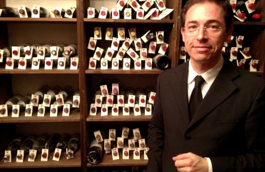 Photogallery






 
Modena’s colonnades, 186 thousand inhabitants and 3 restaurants with at least one Michelin star: Hostaria del Mare (1), Erba del Re (1) and Osteria Francescana (3 stars), our destination
 








Yellow and red tones prevail








The city still bears the signs of the May 2012 earthquake. On May 4th 2013, the day of our visit, a 3.8 magnitude earthquake was registered













By chance, Giuseppe Palmieri, maître and sommelier, appears from the grey door








Palmieri, 38, born in Matera. His first service in Francescana was on September 12th 2000








The old entrance to the restaurant, at number 24 in Via della Stella - as on the opening in 1995. It changed in September 2012: today you enter from number 22. Funnily enough, Google Maps is still set on the old entrance








The present entrance doors








Let’s start








After the latest renovations, the transit areas inside the Osteria appear as a contemporary art gallery








Mario Schifano’s world map








"Tourists", Maurizio Cattelan’s famous pigeons








Underneath the pigeons, Gavin Turk’s “Trashbag”








Three rooms, 12 tables, between 20 to 35 guests. 40% guests are Italian








Every table is illuminated by Davide Groppi’s Sampei lamp: if tables are moved, light follows








Francescana receives 150 reservations every day. But it also suffers from clients not showing up: on average, one table every week is booked but then guests don’t come








Right behind the kitchen, there’s the prêt-à-porter cellar








"In the central cellar, we only keep great vintages and larger bottles of what we consider to be great wines", Beppe Palmieri explains








1,600 wines are listed at Osteria Francescana, with a deep wine list which includes different vintages of the same wine








"A true celebration of wine "








The Ferrari coat, hanging in the cellar: Maranello is only 17 km away from Modena








Jean Todt, Michael Schumacher, Fernando Alonso: Ferrari’s “prancing horse” is at home in Via Stella








Gabrio Bini’s wines, from Pantelleria, a real fetish for Palmieri













Hanging from the ceiling, a nice selection of cured meats from Emilia








Bread made with mother yeast, the premise to a journey which will alternate great classics with very contemporary dishes








Massimo Bottura. Fifty years old last September, he is chef since 1986, the year of Trattoria del Campazzo in Nonantola. His first masters: Lidia Cristoni and Georges Cogny








He’s glowing: a few days ago his restaurant climbed, for the first time, onto the podium of the World's 50Best, a prize that is acquiring an increasing weight and authority. "The thing that makes me the happiest", he says, "is not so much the third place, but the fact that we’ve been in the highest positions for a few years now". True: 13th in 2009, 6th in 2010, 4th in 2011, 5th in 2012, 3rd in 2013








The now famous grey New Balance 993, a real emblem for the chef, friend of Jason Weis, president of the company in Massachusetts. The insole, however, is local: "In Emilia the sector is state-of-the-art", he says








"Are we ready?"








Almond granita with capers, bergamot and coffee cream 
Bottura and Palmieri’s journey across Italy starts from the bottom. And sails off from the Sicilian inland, with a classic granita which in Modena crumbles Adria-style, the wall that divides sweet from savoury, using the picklock of bitterness: Pantelleria capers, wild oregano but also bergamot, a coffee concentrate and vanilla scented salt. To pair with the first part of the meal, Sorriso di Cielo malvasia dei colli piacentini








Mediterranean Macaroon 
Next to the granita, two peculiar macaroons: the first is made with minced anchovies and sardines, the second with oysters and seaweeds. This is a classic scheme in Bottura’scuisine: his ironic turning the order of the dishes, from starter to dessert, upside down, and using popular raw materials instead of ingredients that are emblematic of élite cuisine. «While feet are sinking in the ground, the head is free to move everywhere», is one of his most famous quotes








Tempura of freshwater aulla with carpione ice-cream
Carpione ice-cream on a tempura of freshwater aulla – these fish are similar and slightly bigger than whitebait. The tempura is made by quickly placing the cold batter in boiling oil








Bread and croissants








Grissini








Baccalà Mare Nostrum 
We move up the Tyrrhenian sea to find this salted codfish cooked at low temperature and then seasoned with a touch of Naples and the Amalfi coast, that is to say with an emulsion made with hot oil with tomato vegetal liquid, olives, the zest of Sorrento’s super lemons and some anchovy colatura. These aromas crack with the scented bread on top





