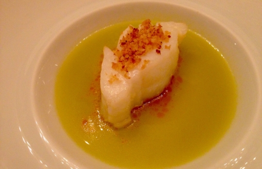 Photogallery






 
Modena’s colonnades, 186 thousand inhabitants and 3 restaurants with at least one Michelin star: Hostaria del Mare (1), Erba del Re (1) and Osteria Francescana (3 stars), our destination
 








Yellow and red tones prevail








The city still bears the signs of the May 2012 earthquake. On May 4th 2013, the day of our visit, a 3.8 magnitude earthquake was registered













By chance, Giuseppe Palmieri, maître and sommelier, appears from the grey door








Palmieri, 38, born in Matera. His first service in Francescana was on September 12th 2000








The old entrance to the restaurant, at number 24 in Via della Stella - as on the opening in 1995. It changed in September 2012: today you enter from number 22. Funnily enough, Google Maps is still set on the old entrance








The present entrance doors








Let’s start








After the latest renovations, the transit areas inside the Osteria appear as a contemporary art gallery








Mario Schifano’s world map








"Tourists", Maurizio Cattelan’s famous pigeons








Underneath the pigeons, Gavin Turk’s “Trashbag”








Three rooms, 12 tables, between 20 to 35 guests. 40% guests are Italian








Every table is illuminated by Davide Groppi’s Sampei lamp: if tables are moved, light follows








Francescana receives 150 reservations every day. But it also suffers from clients not showing up: on average, one table every week is booked but then guests don’t come








Right behind the kitchen, there’s the prêt-à-porter cellar








"In the central cellar, we only keep great vintages and larger bottles of what we consider to be great wines", Beppe Palmieri explains








1,600 wines are listed at Osteria Francescana, with a deep wine list which includes different vintages of the same wine








"A true celebration of wine "








The Ferrari coat, hanging in the cellar: Maranello is only 17 km away from Modena








Jean Todt, Michael Schumacher, Fernando Alonso: Ferrari’s “prancing horse” is at home in Via Stella








Gabrio Bini’s wines, from Pantelleria, a real fetish for Palmieri













Hanging from the ceiling, a nice selection of cured meats from Emilia








Bread made with mother yeast, the premise to a journey which will alternate great classics with very contemporary dishes








Massimo Bottura. Fifty years old last September, he is chef since 1986, the year of Trattoria del Campazzo in Nonantola. His first masters: Lidia Cristoni and Georges Cogny








He’s glowing: a few days ago his restaurant climbed, for the first time, onto the podium of the World's 50Best, a prize that is acquiring an increasing weight and authority. "The thing that makes me the happiest", he says, "is not so much the third place, but the fact that we’ve been in the highest positions for a few years now". True: 13th in 2009, 6th in 2010, 4th in 2011, 5th in 2012, 3rd in 2013








The now famous grey New Balance 993, a real emblem for the chef, friend of Jason Weis, president of the company in Massachusetts. The insole, however, is local: "In Emilia the sector is state-of-the-art", he says








"Are we ready?"








Almond granita with capers, bergamot and coffee cream 
Bottura and Palmieri’s journey across Italy starts from the bottom. And sails off from the Sicilian inland, with a classic granita which in Modena crumbles Adria-style, the wall that divides sweet from savoury, using the picklock of bitterness: Pantelleria capers, wild oregano but also bergamot, a coffee concentrate and vanilla scented salt. To pair with the first part of the meal, Sorriso di Cielo malvasia dei colli piacentini








Mediterranean Macaroon 
Next to the granita, two peculiar macaroons: the first is made with minced anchovies and sardines, the second with oysters and seaweeds. This is a classic scheme in Bottura’scuisine: his ironic turning the order of the dishes, from starter to dessert, upside down, and using popular raw materials instead of ingredients that are emblematic of élite cuisine. «While feet are sinking in the ground, the head is free to move everywhere», is one of his most famous quotes








Tempura of freshwater aulla with carpione ice-cream
Carpione ice-cream on a tempura of freshwater aulla – these fish are similar and slightly bigger than whitebait. The tempura is made by quickly placing the cold batter in boiling oil








Bread and croissants








Grissini





