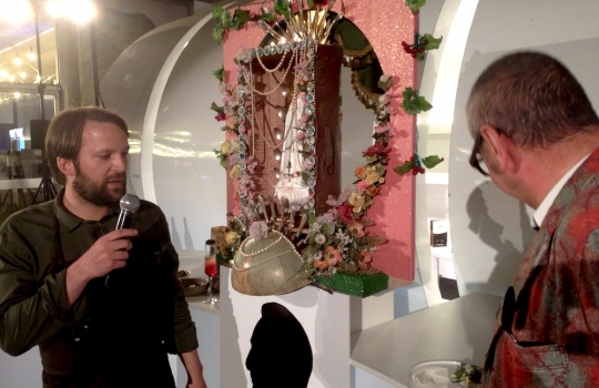 Photogallery






With 250thousand inhabitants, Gent (or Gand) is the third largest city in Belgium. With its canals and its laid back life, it competes with Bruges for the title most beautiful city in the Flanders 








The Sunday began at the Flemish Food Fest, a festival in which everyone was grilling all sorts of food. In the photo, the chef table with many of the chefs that were to be the protagonists of the Gelinaz! dinner








Colagreco, Redzepi and the kitchen-van. The location was kept secret until the beginning of the show, at around 7 pm








The two long tables set at the Icc in Gent. Three shifts: 1-8, 9-16, 17-24. We were so lucky we enjoyed them all








In the kitchen, works to dismember the chickens from Gent begin








"Even I don’t know what will happen tonight. And please remember: this is a performance, not a dinner", says Andrea Petrini, founder and curator of the event named after chef Fulvio Pieran-gelinaz and by Gorillaz, the temporary band that Blur’s Damon Albarn creates whenever he feels like it. The black sculpture underneath the Madonna is that of    Philippe Édouard Cauderlier (Antwerp, 1812-1887)








It all starts by quoting Kubrick and Eyes Wide Shot... Each dish is a song. And each of the three acts is separated by various artistic performances. In the dining room, men act as nothing is going on in front of their partners








First dish of the Gelinaz evening, Philippe Edouard Cauderlier’s Cold-hot chicken timbale, the original recipe from     1861. Roger Souvereyns of Scholteshof in Stevoort had the honour of performing it at the Icc in Gent








Inaki Aizpitarte     ’s Royal chicken kir, using all the ingredients in the original recipe. The wine is diluted in the chicken stock. The dish arrives together with     Wu Tang Clan’s rap








Anataoly Komm of Varvary in Moscow, lets us taste his Maki Roll behind the scenes








Komm’s Maki roll: chicken and vegetables wrapped in a turnip leaf. The sauce is made with walnuts, a Caucasian tradition








Agata Felluga ’s Lotus timbale. She’s the Italian sous chef at Chateaubriand in Paris, with a previous experience at Pascal Barbot’sAstrance. The dish is inspired by a Japanese sticky rice recipe, where the rice is cooked in a lotus leaf. Here, instead, there’s    Cauderlier’s chicken, together with miso, tamarind syrup, pork fat, soy sauce. A very complex dish.








Left, 32 year old Agata Felluga, born in Rome and adopted by the Ville Lumiére








Petter Nilsson’s Bread chicken, from the Gazzetta in Paris. It is made with all the cereals hens eat during their life: corn, hulled wheat, barley, rye and wheat. The photo of the bag is a portrait of the Danish chef’s creation








Massimo Bottura     is not in Gent, however, in a coup de theatre, his brother Paolo takes his place, here on the left with Alberto Buratti,     pastry-chef at Osteria Francescana. The chef from Modena explains in a video the reason behind his absence: "In Modena, his team is so finely     tuned that even my car-salesman brother can take my place", he jokes








Even in Bottura’s dish there’s no traditional chicken: it’s called Chicken, chicken, where are you? It is the re-interpretation     of the classic chicken salad, with a stock made with roasted chicken below, and a cotechino (cooked pork sausage) and agar-agar gelatine with very small dices of peas, carrots, potatoes, red and yellow peppers, onions, tomatoes... in the background, "What about the noise?" by    John Cage strikes us








Pea tendrils with chicken and mint aspic     by Blaine Wetzel, once a pupil of Redzepi, today back home in Lummi Island, a paradise in the middle of nowhere, in     Washington state. The tendrils are grilled. A great dish, with a super balance between smoke, balsamic and acid notes








Chia and chicken with tiger milk, turnips and coca leaves , that is to say "The chicken of Gent meets South America", a journey of the mind, from the Pacific ocean to the Andes to the Amazon forest led by Peruvian    Virgilio Martinez








Virgilio Martinez     at work with Alberto Buratti








Chicken liver, scallion with tarragon, turnip and toasted cauliflower stock by Basque Josean Alija








French-Spanish journalist Maria Canabal and Josean Martinez Alija








Poulet-mayo by Bertrand Grébaut of   Septime in Paris, a cold entrée with all the ingredients of the original recipe. In the background, Rufus Thomas ’s r 'n' b with "Do the funky chicken"








Reneè Redzepi has no doubt when it comes to which is the best part of the chicken: the skin. Half of the guest, as it turned out, agreed with him





