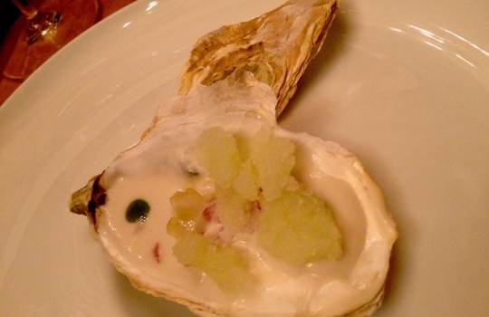 Photogallery






 
Modena’s colonnades, 186 thousand inhabitants and 3 restaurants with at least one Michelin star: Hostaria del Mare (1), Erba del Re (1) and Osteria Francescana (3 stars), our destination
 








Yellow and red tones prevail








The city still bears the signs of the May 2012 earthquake. On May 4th 2013, the day of our visit, a 3.8 magnitude earthquake was registered













By chance, Giuseppe Palmieri, maître and sommelier, appears from the grey door








Palmieri, 38, born in Matera. His first service in Francescana was on September 12th 2000








The old entrance to the restaurant, at number 24 in Via della Stella - as on the opening in 1995. It changed in September 2012: today you enter from number 22. Funnily enough, Google Maps is still set on the old entrance








The present entrance doors








Let’s start








After the latest renovations, the transit areas inside the Osteria appear as a contemporary art gallery








Mario Schifano’s world map








"Tourists", Maurizio Cattelan’s famous pigeons








Underneath the pigeons, Gavin Turk’s “Trashbag”








Three rooms, 12 tables, between 20 to 35 guests. 40% guests are Italian








Every table is illuminated by Davide Groppi’s Sampei lamp: if tables are moved, light follows








Francescana receives 150 reservations every day. But it also suffers from clients not showing up: on average, one table every week is booked but then guests don’t come








Right behind the kitchen, there’s the prêt-à-porter cellar








"In the central cellar, we only keep great vintages and larger bottles of what we consider to be great wines", Beppe Palmieri explains








1,600 wines are listed at Osteria Francescana, with a deep wine list which includes different vintages of the same wine








"A true celebration of wine "








The Ferrari coat, hanging in the cellar: Maranello is only 17 km away from Modena








Jean Todt, Michael Schumacher, Fernando Alonso: Ferrari’s “prancing horse” is at home in Via Stella








Gabrio Bini’s wines, from Pantelleria, a real fetish for Palmieri













Hanging from the ceiling, a nice selection of cured meats from Emilia








Bread made with mother yeast, the premise to a journey which will alternate great classics with very contemporary dishes








Massimo Bottura. Fifty years old last September, he is chef since 1986, the year of Trattoria del Campazzo in Nonantola. His first masters: Lidia Cristoni and Georges Cogny








He’s glowing: a few days ago his restaurant climbed, for the first time, onto the podium of the World's 50Best, a prize that is acquiring an increasing weight and authority. "The thing that makes me the happiest", he says, "is not so much the third place, but the fact that we’ve been in the highest positions for a few years now". True: 13th in 2009, 6th in 2010, 4th in 2011, 5th in 2012, 3rd in 2013








The now famous grey New Balance 993, a real emblem for the chef, friend of Jason Weis, president of the company in Massachusetts. The insole, however, is local: "In Emilia the sector is state-of-the-art", he says








"Are we ready?"








Almond granita with capers, bergamot and coffee cream 
Bottura and Palmieri’s journey across Italy starts from the bottom. And sails off from the Sicilian inland, with a classic granita which in Modena crumbles Adria-style, the wall that divides sweet from savoury, using the picklock of bitterness: Pantelleria capers, wild oregano but also bergamot, a coffee concentrate and vanilla scented salt. To pair with the first part of the meal, Sorriso di Cielo malvasia dei colli piacentini








Mediterranean Macaroon 
Next to the granita, two peculiar macaroons: the first is made with minced anchovies and sardines, the second with oysters and seaweeds. This is a classic scheme in Bottura’scuisine: his ironic turning the order of the dishes, from starter to dessert, upside down, and using popular raw materials instead of ingredients that are emblematic of élite cuisine. «While feet are sinking in the ground, the head is free to move everywhere», is one of his most famous quotes








Tempura of freshwater aulla with carpione ice-cream
Carpione ice-cream on a tempura of freshwater aulla – these fish are similar and slightly bigger than whitebait. The tempura is made by quickly placing the cold batter in boiling oil








Bread and croissants








Grissini








Baccalà Mare Nostrum 
We move up the Tyrrhenian sea to find this salted codfish cooked at low temperature and then seasoned with a touch of Naples and the Amalfi coast, that is to say with an emulsion made with hot oil with tomato vegetal liquid, olives, the zest of Sorrento’s super lemons and some anchovy colatura. These aromas crack with the scented bread on top








40 year old Denis Bretta explains the dishes as if from a book. Once at Restaurant Fini in Modena, for the past year and a half he’s been the manager responsible for the service in the restaurant. But don’t ask Palmieri to explain his role, as he’s abolished all hierarchies: "In our restaurant there are no commis or chef de rang. At a time when titles are so abused, I prefer for us to be all colleagues. All waiters."








How to burn sardines in three days 
Another journey, another horizon, the Adriatic Sea between Romagna and Ancona. A new camouflaged expression: these are not sardines (and they aren’t burnt either) but they are small sea-rock mullet, marinated for 3 days, then seared on one side on a grill, and filled like a sandwich with some (very sweet) scampi cream, and covered with vegetable ashes, aromatic herbs and lemon zest. “I wanted to make fun of the Marche-Romagna habit of grilling everything”, the chef says, “with lemon, garlic and parsley always added later to fix everything”









Rice, between fresh and sea water 
Recalling the Po estuary with freshwater and brackish sensations. The freshwater flavours cover the surface of the oyster which prevails on the river bed. And in the end, catfish, carp, vegetable chlorophyll and carpione win once again








 
A journey to Modena: Adriatic eel, polenta, Campanine apple jelly and saba
Another fluvial odyssey, presented for the first time at Identità Milano in 2011. The Adriatic eel travels across Veneto (with the polenta cream), Mantua (the Campanine apple jelly), the countryside of Modena (with the Saba lacquering, that is to say the mother of Aceto Balsamico) and stops in the centre of Modena (blackened powdered onion, a mimesis of the town’s canals)
 





