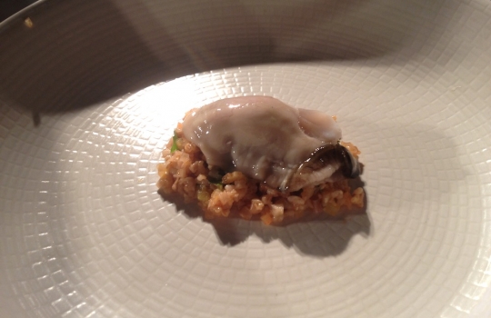 Photogallery






With 250thousand inhabitants, Gent (or Gand) is the third largest city in Belgium. With its canals and its laid back life, it competes with Bruges for the title most beautiful city in the Flanders 








The Sunday began at the Flemish Food Fest, a festival in which everyone was grilling all sorts of food. In the photo, the chef table with many of the chefs that were to be the protagonists of the Gelinaz! dinner








Colagreco, Redzepi and the kitchen-van. The location was kept secret until the beginning of the show, at around 7 pm








The two long tables set at the Icc in Gent. Three shifts: 1-8, 9-16, 17-24. We were so lucky we enjoyed them all








In the kitchen, works to dismember the chickens from Gent begin








"Even I don’t know what will happen tonight. And please remember: this is a performance, not a dinner", says Andrea Petrini, founder and curator of the event named after chef Fulvio Pieran-gelinaz and by Gorillaz, the temporary band that Blur’s Damon Albarn creates whenever he feels like it. The black sculpture underneath the Madonna is that of    Philippe Édouard Cauderlier (Antwerp, 1812-1887)








It all starts by quoting Kubrick and Eyes Wide Shot... Each dish is a song. And each of the three acts is separated by various artistic performances. In the dining room, men act as nothing is going on in front of their partners








First dish of the Gelinaz evening, Philippe Edouard Cauderlier’s Cold-hot chicken timbale, the original recipe from     1861. Roger Souvereyns of Scholteshof in Stevoort had the honour of performing it at the Icc in Gent








Inaki Aizpitarte     ’s Royal chicken kir, using all the ingredients in the original recipe. The wine is diluted in the chicken stock. The dish arrives together with     Wu Tang Clan’s rap








Anataoly Komm of Varvary in Moscow, lets us taste his Maki Roll behind the scenes








Komm’s Maki roll: chicken and vegetables wrapped in a turnip leaf. The sauce is made with walnuts, a Caucasian tradition








Agata Felluga ’s Lotus timbale. She’s the Italian sous chef at Chateaubriand in Paris, with a previous experience at Pascal Barbot’sAstrance. The dish is inspired by a Japanese sticky rice recipe, where the rice is cooked in a lotus leaf. Here, instead, there’s    Cauderlier’s chicken, together with miso, tamarind syrup, pork fat, soy sauce. A very complex dish.








Left, 32 year old Agata Felluga, born in Rome and adopted by the Ville Lumiére








Petter Nilsson’s Bread chicken, from the Gazzetta in Paris. It is made with all the cereals hens eat during their life: corn, hulled wheat, barley, rye and wheat. The photo of the bag is a portrait of the Danish chef’s creation








Massimo Bottura     is not in Gent, however, in a coup de theatre, his brother Paolo takes his place, here on the left with Alberto Buratti,     pastry-chef at Osteria Francescana. The chef from Modena explains in a video the reason behind his absence: "In Modena, his team is so finely     tuned that even my car-salesman brother can take my place", he jokes








Even in Bottura’s dish there’s no traditional chicken: it’s called Chicken, chicken, where are you? It is the re-interpretation     of the classic chicken salad, with a stock made with roasted chicken below, and a cotechino (cooked pork sausage) and agar-agar gelatine with very small dices of peas, carrots, potatoes, red and yellow peppers, onions, tomatoes... in the background, "What about the noise?" by    John Cage strikes us








Pea tendrils with chicken and mint aspic     by Blaine Wetzel, once a pupil of Redzepi, today back home in Lummi Island, a paradise in the middle of nowhere, in     Washington state. The tendrils are grilled. A great dish, with a super balance between smoke, balsamic and acid notes








Chia and chicken with tiger milk, turnips and coca leaves , that is to say "The chicken of Gent meets South America", a journey of the mind, from the Pacific ocean to the Andes to the Amazon forest led by Peruvian    Virgilio Martinez








Virgilio Martinez     at work with Alberto Buratti








Chicken liver, scallion with tarragon, turnip and toasted cauliflower stock by Basque Josean Alija








French-Spanish journalist Maria Canabal and Josean Martinez Alija








Poulet-mayo by Bertrand Grébaut of   Septime in Paris, a cold entrée with all the ingredients of the original recipe. In the background, Rufus Thomas ’s r 'n' b with "Do the funky chicken"








Reneè Redzepi has no doubt when it comes to which is the best part of the chicken: the skin. Half of the guest, as it turned out, agreed with him








Redzepi, on the left, explains his passion for chicken, discovered when he was a child in Macedonia. "I had to prepare this dish at home because it is fucking complicated"








Here it is: it’s not exactly chicken skin, but the “skin” made with a stock prepared using all the ingredients in Cauderlier’s recipe, removing the froth. A single, fantastic morsel, one of the many intervals that compose the first part of a dinner at Noma








We peek into the iPad of Italian Emilia Terragni who works for Phaidon in London, and is sitting at the table next to     ours, and we see a juicy preview: the triple format of Renè Redzepi’s next book, which will be out in November. It’s a sort of diary, an     intimate one, too, in which he explains how difficult dealing with the limelight is








The monumental “skyscrapers” of Six degrees of separations, Davide Scabin’s fantastic idea








In Scabin’s dish, there are 6 of the ingredients in the original recipe, but cooked separately, 6 "morsels" composed by: 1. Porto gelatine with carrot, pea and pea gelatine 2. Chicken mousse filled with livers and two pop corns to keep them firm 3. A pork jelly with tarragon vinegar 4. Cucumber roll with French beans and soy sauce jelly 5. Pork feet and tongue gelatine. And the 6th? Sorry, no response. On the left we find a light chicken royale served in a Martini glass








The Combal.Zero Trio, from Rivoli. In the background, the chosen music was Frank Zappa’s dystonic Bolero





