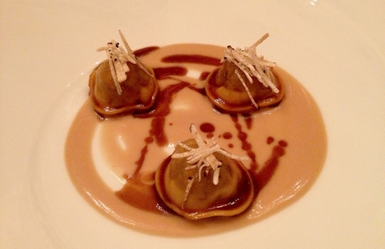 Photogallery






 
Modena’s colonnades, 186 thousand inhabitants and 3 restaurants with at least one Michelin star: Hostaria del Mare (1), Erba del Re (1) and Osteria Francescana (3 stars), our destination
 








Yellow and red tones prevail








The city still bears the signs of the May 2012 earthquake. On May 4th 2013, the day of our visit, a 3.8 magnitude earthquake was registered













By chance, Giuseppe Palmieri, maître and sommelier, appears from the grey door








Palmieri, 38, born in Matera. His first service in Francescana was on September 12th 2000








The old entrance to the restaurant, at number 24 in Via della Stella - as on the opening in 1995. It changed in September 2012: today you enter from number 22. Funnily enough, Google Maps is still set on the old entrance








The present entrance doors








Let’s start








After the latest renovations, the transit areas inside the Osteria appear as a contemporary art gallery








Mario Schifano’s world map








"Tourists", Maurizio Cattelan’s famous pigeons








Underneath the pigeons, Gavin Turk’s “Trashbag”








Three rooms, 12 tables, between 20 to 35 guests. 40% guests are Italian








Every table is illuminated by Davide Groppi’s Sampei lamp: if tables are moved, light follows








Francescana receives 150 reservations every day. But it also suffers from clients not showing up: on average, one table every week is booked but then guests don’t come








Right behind the kitchen, there’s the prêt-à-porter cellar








"In the central cellar, we only keep great vintages and larger bottles of what we consider to be great wines", Beppe Palmieri explains








1,600 wines are listed at Osteria Francescana, with a deep wine list which includes different vintages of the same wine








"A true celebration of wine "








The Ferrari coat, hanging in the cellar: Maranello is only 17 km away from Modena








Jean Todt, Michael Schumacher, Fernando Alonso: Ferrari’s “prancing horse” is at home in Via Stella








Gabrio Bini’s wines, from Pantelleria, a real fetish for Palmieri













Hanging from the ceiling, a nice selection of cured meats from Emilia








Bread made with mother yeast, the premise to a journey which will alternate great classics with very contemporary dishes








Massimo Bottura. Fifty years old last September, he is chef since 1986, the year of Trattoria del Campazzo in Nonantola. His first masters: Lidia Cristoni and Georges Cogny








He’s glowing: a few days ago his restaurant climbed, for the first time, onto the podium of the World's 50Best, a prize that is acquiring an increasing weight and authority. "The thing that makes me the happiest", he says, "is not so much the third place, but the fact that we’ve been in the highest positions for a few years now". True: 13th in 2009, 6th in 2010, 4th in 2011, 5th in 2012, 3rd in 2013








The now famous grey New Balance 993, a real emblem for the chef, friend of Jason Weis, president of the company in Massachusetts. The insole, however, is local: "In Emilia the sector is state-of-the-art", he says








"Are we ready?"








Almond granita with capers, bergamot and coffee cream 
Bottura and Palmieri’s journey across Italy starts from the bottom. And sails off from the Sicilian inland, with a classic granita which in Modena crumbles Adria-style, the wall that divides sweet from savoury, using the picklock of bitterness: Pantelleria capers, wild oregano but also bergamot, a coffee concentrate and vanilla scented salt. To pair with the first part of the meal, Sorriso di Cielo malvasia dei colli piacentini








Mediterranean Macaroon 
Next to the granita, two peculiar macaroons: the first is made with minced anchovies and sardines, the second with oysters and seaweeds. This is a classic scheme in Bottura’scuisine: his ironic turning the order of the dishes, from starter to dessert, upside down, and using popular raw materials instead of ingredients that are emblematic of élite cuisine. «While feet are sinking in the ground, the head is free to move everywhere», is one of his most famous quotes








Tempura of freshwater aulla with carpione ice-cream
Carpione ice-cream on a tempura of freshwater aulla – these fish are similar and slightly bigger than whitebait. The tempura is made by quickly placing the cold batter in boiling oil








Bread and croissants








Grissini








Baccalà Mare Nostrum 
We move up the Tyrrhenian sea to find this salted codfish cooked at low temperature and then seasoned with a touch of Naples and the Amalfi coast, that is to say with an emulsion made with hot oil with tomato vegetal liquid, olives, the zest of Sorrento’s super lemons and some anchovy colatura. These aromas crack with the scented bread on top








40 year old Denis Bretta explains the dishes as if from a book. Once at Restaurant Fini in Modena, for the past year and a half he’s been the manager responsible for the service in the restaurant. But don’t ask Palmieri to explain his role, as he’s abolished all hierarchies: "In our restaurant there are no commis or chef de rang. At a time when titles are so abused, I prefer for us to be all colleagues. All waiters."








How to burn sardines in three days 
Another journey, another horizon, the Adriatic Sea between Romagna and Ancona. A new camouflaged expression: these are not sardines (and they aren’t burnt either) but they are small sea-rock mullet, marinated for 3 days, then seared on one side on a grill, and filled like a sandwich with some (very sweet) scampi cream, and covered with vegetable ashes, aromatic herbs and lemon zest. “I wanted to make fun of the Marche-Romagna habit of grilling everything”, the chef says, “with lemon, garlic and parsley always added later to fix everything”









Rice, between fresh and sea water 
Recalling the Po estuary with freshwater and brackish sensations. The freshwater flavours cover the surface of the oyster which prevails on the river bed. And in the end, catfish, carp, vegetable chlorophyll and carpione win once again








 
A journey to Modena: Adriatic eel, polenta, Campanine apple jelly and saba
Another fluvial odyssey, presented for the first time at Identità Milano in 2011. The Adriatic eel travels across Veneto (with the polenta cream), Mantua (the Campanine apple jelly), the countryside of Modena (with the Saba lacquering, that is to say the mother of Aceto Balsamico) and stops in the centre of Modena (blackened powdered onion, a mimesis of the town’s canals)
 








Normandy
That is to say pre-salè lamb (hanging for 20 days) with an emulsion of oyster water, fresh seaweeds and caviar. On top, a green apple granita that recalls cider. “This is our tribute to Normandy”, Bretta says, “in Modena there are no enchanted beaches or breath-taking mountain tops. From Via Stella you can’t even see the Torre Ghirlandina. What guides us is the persistant strength of ideas, woven into the culture and into memories”








Giovanni Boroni’s Genziana from Trentino. A brilliant idea by Palmieri that acts as a bridge between the two dishes, Normandy (previous picture) and Think Green (next one). This distillate plays an immediate contrast with the sea-character of the first dish: "To me, harmony is what is left after a confrontation", B.P. says. And the confrontation is followed by the thought that spurs from the following match: water is added to the Genziana and the palate surprisingly longs to gulp it all. This is the perfect vehicle for the aromas of the genziana and "gives length" to the minerality of the wild herbs. "This serves to recall water, our true source of richness". Brilliant








Think Green
Vegetal chlorophyll, asparagus tops, pea cream, mushrooms, truffle, flowers, aromatic herbs and Parmigiano Reggiano curd. The idea of this dish came after observing the biological cycle of grazing cows, 4 seasons that sum up all of life. “This is what the cow eats, and what it returns to us, thanks to an extraordinary milk”, Bottura adds








Five ages of Parmigiano Reggiano 
A great classic from 1996, "when the textures in fact were 3", Palmieri points out. Today they are 5: 4 month ageing cream, 30 month demi-soufflè, 36 month mousse, 40 month crispy wafer, on top, “air” of 50 month Parmesan. (photo by Le Saucier)








A compression of pasta and beans 
Another great classic, this is a journey across Bottura’s experiences in the kitchen: Creme royal with pork rind, beans and foie gras (French tradition), rosemary air (the Spanish vanguard) and Parmesan crust (the Emilian essence) used instead of pasta. “This is a dish based on evolution, not revolution. I compressed my grandmother between Alain Ducasse and Ferran Adrià”








Snails under the grapevines 
Snails, aromatic chlorophyll on a bed of wild vegetables and herbs, with mushrooms, truffle and bulbs. After the cow’s life cycle, here comes that of the snail. "Once again, we’re chewing the territory: the best snails slither in the vineyards, among mineral, sapid and acid aromas"





