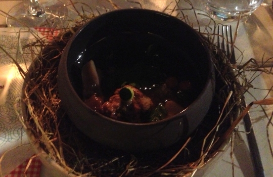 Photogallery






With 250thousand inhabitants, Gent (or Gand) is the third largest city in Belgium. With its canals and its laid back life, it competes with Bruges for the title most beautiful city in the Flanders 








The Sunday began at the Flemish Food Fest, a festival in which everyone was grilling all sorts of food. In the photo, the chef table with many of the chefs that were to be the protagonists of the Gelinaz! dinner








Colagreco, Redzepi and the kitchen-van. The location was kept secret until the beginning of the show, at around 7 pm








The two long tables set at the Icc in Gent. Three shifts: 1-8, 9-16, 17-24. We were so lucky we enjoyed them all








In the kitchen, works to dismember the chickens from Gent begin








"Even I don’t know what will happen tonight. And please remember: this is a performance, not a dinner", says Andrea Petrini, founder and curator of the event named after chef Fulvio Pieran-gelinaz and by Gorillaz, the temporary band that Blur’s Damon Albarn creates whenever he feels like it. The black sculpture underneath the Madonna is that of    Philippe Édouard Cauderlier (Antwerp, 1812-1887)








It all starts by quoting Kubrick and Eyes Wide Shot... Each dish is a song. And each of the three acts is separated by various artistic performances. In the dining room, men act as nothing is going on in front of their partners








First dish of the Gelinaz evening, Philippe Edouard Cauderlier’s Cold-hot chicken timbale, the original recipe from     1861. Roger Souvereyns of Scholteshof in Stevoort had the honour of performing it at the Icc in Gent








Inaki Aizpitarte     ’s Royal chicken kir, using all the ingredients in the original recipe. The wine is diluted in the chicken stock. The dish arrives together with     Wu Tang Clan’s rap








Anataoly Komm of Varvary in Moscow, lets us taste his Maki Roll behind the scenes








Komm’s Maki roll: chicken and vegetables wrapped in a turnip leaf. The sauce is made with walnuts, a Caucasian tradition








Agata Felluga ’s Lotus timbale. She’s the Italian sous chef at Chateaubriand in Paris, with a previous experience at Pascal Barbot’sAstrance. The dish is inspired by a Japanese sticky rice recipe, where the rice is cooked in a lotus leaf. Here, instead, there’s    Cauderlier’s chicken, together with miso, tamarind syrup, pork fat, soy sauce. A very complex dish.








Left, 32 year old Agata Felluga, born in Rome and adopted by the Ville Lumiére








Petter Nilsson’s Bread chicken, from the Gazzetta in Paris. It is made with all the cereals hens eat during their life: corn, hulled wheat, barley, rye and wheat. The photo of the bag is a portrait of the Danish chef’s creation








Massimo Bottura     is not in Gent, however, in a coup de theatre, his brother Paolo takes his place, here on the left with Alberto Buratti,     pastry-chef at Osteria Francescana. The chef from Modena explains in a video the reason behind his absence: "In Modena, his team is so finely     tuned that even my car-salesman brother can take my place", he jokes








Even in Bottura’s dish there’s no traditional chicken: it’s called Chicken, chicken, where are you? It is the re-interpretation     of the classic chicken salad, with a stock made with roasted chicken below, and a cotechino (cooked pork sausage) and agar-agar gelatine with very small dices of peas, carrots, potatoes, red and yellow peppers, onions, tomatoes... in the background, "What about the noise?" by    John Cage strikes us








Pea tendrils with chicken and mint aspic     by Blaine Wetzel, once a pupil of Redzepi, today back home in Lummi Island, a paradise in the middle of nowhere, in     Washington state. The tendrils are grilled. A great dish, with a super balance between smoke, balsamic and acid notes








Chia and chicken with tiger milk, turnips and coca leaves , that is to say "The chicken of Gent meets South America", a journey of the mind, from the Pacific ocean to the Andes to the Amazon forest led by Peruvian    Virgilio Martinez








Virgilio Martinez     at work with Alberto Buratti








Chicken liver, scallion with tarragon, turnip and toasted cauliflower stock by Basque Josean Alija








French-Spanish journalist Maria Canabal and Josean Martinez Alija








Poulet-mayo by Bertrand Grébaut of   Septime in Paris, a cold entrée with all the ingredients of the original recipe. In the background, Rufus Thomas ’s r 'n' b with "Do the funky chicken"








Reneè Redzepi has no doubt when it comes to which is the best part of the chicken: the skin. Half of the guest, as it turned out, agreed with him








Redzepi, on the left, explains his passion for chicken, discovered when he was a child in Macedonia. "I had to prepare this dish at home because it is fucking complicated"








Here it is: it’s not exactly chicken skin, but the “skin” made with a stock prepared using all the ingredients in Cauderlier’s recipe, removing the froth. A single, fantastic morsel, one of the many intervals that compose the first part of a dinner at Noma








We peek into the iPad of Italian Emilia Terragni who works for Phaidon in London, and is sitting at the table next to     ours, and we see a juicy preview: the triple format of Renè Redzepi’s next book, which will be out in November. It’s a sort of diary, an     intimate one, too, in which he explains how difficult dealing with the limelight is








The monumental “skyscrapers” of Six degrees of separations, Davide Scabin’s fantastic idea








In Scabin’s dish, there are 6 of the ingredients in the original recipe, but cooked separately, 6 "morsels" composed by: 1. Porto gelatine with carrot, pea and pea gelatine 2. Chicken mousse filled with livers and two pop corns to keep them firm 3. A pork jelly with tarragon vinegar 4. Cucumber roll with French beans and soy sauce jelly 5. Pork feet and tongue gelatine. And the 6th? Sorry, no response. On the left we find a light chicken royale served in a Martini glass








The Combal.Zero Trio, from Rivoli. In the background, the chosen music was Frank Zappa’s dystonic Bolero








Not a chicken     , in fact it is an oyster with a spicy tabbouleh with pork feet. An extraordinary dish by Daniel Patterson of Coi in San     Francisco. In the background, "Cool Thing", progressive rock by Sonic Youth








Chicken tea by Eneko Atxa. Cooked in infusion in the coffee machine, it includes chicken cut into pieces, carrots, onions, cauliflowers, French beans, baby carrots and edible flowers such as verbena








Basque Eneko Atxa and Chilean colleague Rodolfo Guzman, author of A pork that wanted to be a chicken, a tribute to Massimo Bottura. It’s a Disshert that is to say it is halfway between sweet dessert tones and the grilled ones of a main course








Tireless Mauro Colagreco








His dish is called The chicken that lost its mind (head) and the idea comes from a reflection: why are the children of today always served headless and legless chicken?" I decided to use these ingredients, so as to let today’s kids understand chicken as a whole, hens that are alive and free to run. A stimuli for children to question the origin of our food. Colagreco is soon to become a dad





