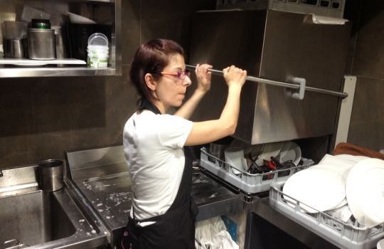 Photogallery






 
Modena’s colonnades, 186 thousand inhabitants and 3 restaurants with at least one Michelin star: Hostaria del Mare (1), Erba del Re (1) and Osteria Francescana (3 stars), our destination
 








Yellow and red tones prevail








The city still bears the signs of the May 2012 earthquake. On May 4th 2013, the day of our visit, a 3.8 magnitude earthquake was registered













By chance, Giuseppe Palmieri, maître and sommelier, appears from the grey door








Palmieri, 38, born in Matera. His first service in Francescana was on September 12th 2000








The old entrance to the restaurant, at number 24 in Via della Stella - as on the opening in 1995. It changed in September 2012: today you enter from number 22. Funnily enough, Google Maps is still set on the old entrance








The present entrance doors








Let’s start








After the latest renovations, the transit areas inside the Osteria appear as a contemporary art gallery








Mario Schifano’s world map








"Tourists", Maurizio Cattelan’s famous pigeons








Underneath the pigeons, Gavin Turk’s “Trashbag”








Three rooms, 12 tables, between 20 to 35 guests. 40% guests are Italian








Every table is illuminated by Davide Groppi’s Sampei lamp: if tables are moved, light follows








Francescana receives 150 reservations every day. But it also suffers from clients not showing up: on average, one table every week is booked but then guests don’t come








Right behind the kitchen, there’s the prêt-à-porter cellar








"In the central cellar, we only keep great vintages and larger bottles of what we consider to be great wines", Beppe Palmieri explains








1,600 wines are listed at Osteria Francescana, with a deep wine list which includes different vintages of the same wine








"A true celebration of wine "








The Ferrari coat, hanging in the cellar: Maranello is only 17 km away from Modena








Jean Todt, Michael Schumacher, Fernando Alonso: Ferrari’s “prancing horse” is at home in Via Stella








Gabrio Bini’s wines, from Pantelleria, a real fetish for Palmieri













Hanging from the ceiling, a nice selection of cured meats from Emilia








Bread made with mother yeast, the premise to a journey which will alternate great classics with very contemporary dishes








Massimo Bottura. Fifty years old last September, he is chef since 1986, the year of Trattoria del Campazzo in Nonantola. His first masters: Lidia Cristoni and Georges Cogny








He’s glowing: a few days ago his restaurant climbed, for the first time, onto the podium of the World's 50Best, a prize that is acquiring an increasing weight and authority. "The thing that makes me the happiest", he says, "is not so much the third place, but the fact that we’ve been in the highest positions for a few years now". True: 13th in 2009, 6th in 2010, 4th in 2011, 5th in 2012, 3rd in 2013








The now famous grey New Balance 993, a real emblem for the chef, friend of Jason Weis, president of the company in Massachusetts. The insole, however, is local: "In Emilia the sector is state-of-the-art", he says








"Are we ready?"








Almond granita with capers, bergamot and coffee cream 
Bottura and Palmieri’s journey across Italy starts from the bottom. And sails off from the Sicilian inland, with a classic granita which in Modena crumbles Adria-style, the wall that divides sweet from savoury, using the picklock of bitterness: Pantelleria capers, wild oregano but also bergamot, a coffee concentrate and vanilla scented salt. To pair with the first part of the meal, Sorriso di Cielo malvasia dei colli piacentini








Mediterranean Macaroon 
Next to the granita, two peculiar macaroons: the first is made with minced anchovies and sardines, the second with oysters and seaweeds. This is a classic scheme in Bottura’scuisine: his ironic turning the order of the dishes, from starter to dessert, upside down, and using popular raw materials instead of ingredients that are emblematic of élite cuisine. «While feet are sinking in the ground, the head is free to move everywhere», is one of his most famous quotes








Tempura of freshwater aulla with carpione ice-cream
Carpione ice-cream on a tempura of freshwater aulla – these fish are similar and slightly bigger than whitebait. The tempura is made by quickly placing the cold batter in boiling oil








Bread and croissants








Grissini








Baccalà Mare Nostrum 
We move up the Tyrrhenian sea to find this salted codfish cooked at low temperature and then seasoned with a touch of Naples and the Amalfi coast, that is to say with an emulsion made with hot oil with tomato vegetal liquid, olives, the zest of Sorrento’s super lemons and some anchovy colatura. These aromas crack with the scented bread on top








40 year old Denis Bretta explains the dishes as if from a book. Once at Restaurant Fini in Modena, for the past year and a half he’s been the manager responsible for the service in the restaurant. But don’t ask Palmieri to explain his role, as he’s abolished all hierarchies: "In our restaurant there are no commis or chef de rang. At a time when titles are so abused, I prefer for us to be all colleagues. All waiters."








How to burn sardines in three days 
Another journey, another horizon, the Adriatic Sea between Romagna and Ancona. A new camouflaged expression: these are not sardines (and they aren’t burnt either) but they are small sea-rock mullet, marinated for 3 days, then seared on one side on a grill, and filled like a sandwich with some (very sweet) scampi cream, and covered with vegetable ashes, aromatic herbs and lemon zest. “I wanted to make fun of the Marche-Romagna habit of grilling everything”, the chef says, “with lemon, garlic and parsley always added later to fix everything”









Rice, between fresh and sea water 
Recalling the Po estuary with freshwater and brackish sensations. The freshwater flavours cover the surface of the oyster which prevails on the river bed. And in the end, catfish, carp, vegetable chlorophyll and carpione win once again








 
A journey to Modena: Adriatic eel, polenta, Campanine apple jelly and saba
Another fluvial odyssey, presented for the first time at Identità Milano in 2011. The Adriatic eel travels across Veneto (with the polenta cream), Mantua (the Campanine apple jelly), the countryside of Modena (with the Saba lacquering, that is to say the mother of Aceto Balsamico) and stops in the centre of Modena (blackened powdered onion, a mimesis of the town’s canals)
 








Normandy
That is to say pre-salè lamb (hanging for 20 days) with an emulsion of oyster water, fresh seaweeds and caviar. On top, a green apple granita that recalls cider. “This is our tribute to Normandy”, Bretta says, “in Modena there are no enchanted beaches or breath-taking mountain tops. From Via Stella you can’t even see the Torre Ghirlandina. What guides us is the persistant strength of ideas, woven into the culture and into memories”








Giovanni Boroni’s Genziana from Trentino. A brilliant idea by Palmieri that acts as a bridge between the two dishes, Normandy (previous picture) and Think Green (next one). This distillate plays an immediate contrast with the sea-character of the first dish: "To me, harmony is what is left after a confrontation", B.P. says. And the confrontation is followed by the thought that spurs from the following match: water is added to the Genziana and the palate surprisingly longs to gulp it all. This is the perfect vehicle for the aromas of the genziana and "gives length" to the minerality of the wild herbs. "This serves to recall water, our true source of richness". Brilliant








Think Green
Vegetal chlorophyll, asparagus tops, pea cream, mushrooms, truffle, flowers, aromatic herbs and Parmigiano Reggiano curd. The idea of this dish came after observing the biological cycle of grazing cows, 4 seasons that sum up all of life. “This is what the cow eats, and what it returns to us, thanks to an extraordinary milk”, Bottura adds








Five ages of Parmigiano Reggiano 
A great classic from 1996, "when the textures in fact were 3", Palmieri points out. Today they are 5: 4 month ageing cream, 30 month demi-soufflè, 36 month mousse, 40 month crispy wafer, on top, “air” of 50 month Parmesan. (photo by Le Saucier)








A compression of pasta and beans 
Another great classic, this is a journey across Bottura’s experiences in the kitchen: Creme royal with pork rind, beans and foie gras (French tradition), rosemary air (the Spanish vanguard) and Parmesan crust (the Emilian essence) used instead of pasta. “This is a dish based on evolution, not revolution. I compressed my grandmother between Alain Ducasse and Ferran Adrià”








Snails under the grapevines 
Snails, aromatic chlorophyll on a bed of wild vegetables and herbs, with mushrooms, truffle and bulbs. After the cow’s life cycle, here comes that of the snail. "Once again, we’re chewing the territory: the best snails slither in the vineyards, among mineral, sapid and acid aromas"








A Frenchman’s dream of making pasta like an Italian 
Or, Ravioli with leeks, foie gras and truffle. We covered this in detail in Identità di Pasta issue number 27








Damijan Podversic’s Ribolla Gialla, a great wine by a wine producer from Gorizia inspired by Josko Gravner. It will support the following dish, without concealing it








A sharp knife is only served now. Another sign of the “allergy” to lengthy chewing that characterises most of contemporary high cuisine








Pigeon hunt 
And over to Bretta: "This is served in a balsamic sauce made with beetroots, which recalls blood. The salad is made with fake leaves, made by cutting out some tubers using some small stamps. These are then compressed in a vacuum with different types of vinegar. The horseradish is grated a few seconds before service, to give some velocity to the pigeon". Irony wins, since "pigeons are not hunted". The bird supplier is Franco Cazzamali from Cremona








Before the dessert, a trip to the restroom: vegetal notes prevail here too








A visit to the kitchen: capon stock








The chef watches over everything, even on the loud music wired wireless from the ceiling. When we get inside, Rod Stewart is screaming "Do you think I'm sexy?"








Meanwhile, the sauces are prepared for the evening service. There’s no break between lunch and dinner. "People sometimes leave at 5 pm because they come here to enjoy the experience of a lifetime", Palmieri reveals, "We work non-stop and every year is worse (or better, that is to say). Don’t ask me anything after midnight, though, because I can’t think straight"








Between dining room and kitchen, today 27 people work at Osteria Francescana. Many of them are interns: "Had I been offered an internship with Ducasse, at the time”, Bottura says, "I would have paid myself". In fact, he really took an internship at the Louis XV in Monte Carlo, in 1992








Leaves 
The journey takes us amidst the forests beds in Umbria: the real leaves change according to the season (black cabbage in winter, red and green basil in spring), they are caramelised and then worked with some chestnut and hazelnut paste, with a vin brulée reduction, chocolate and citrus fruits concentrate...








Magnum of Foie gras (before)
A foie gras terrine, vacuum cooked, covered with powdered toasted hazelnuts and chopped toasted almonds, finished with some apple Balsamic Vinegar. This is possibly Massimo Bottura’s most famous (and copied) dish. Alessandra Meldolesi, in her book "Sei. Autirotratto della cucina italiana d'avanguardia" she writes: "It’s a trompe-l’oeil starter in which a mould unmistakably used in the food industry, encloses the secret of the most exclusive delicacies, foie gras and Aceto Balsamico Tradizionale. This is snack versus high cuisine, dessert versus starter, entremets versus carne: the triple antiphrasis manages to get a smile"








Magnum of Foie Gras (after)
Ehm








Oops, a broken lemon tart 
A lemon tart with lemon zabaglione, lemongrass ice-cream, lemon confit, capers and bergamot (with the latter, we go back to where we had started from). This is the last dish of a masterly journey








Sous chef
Here are the staff. We start with Yoji Tokuyoshi, 35, from Japan, for 8 years at Osteria Francescana. He’s just back from the Postrivoro for Slow Fish








Managing orders
Takahiko Kondo, from Japan








Starters
Davide Di Fabio, 27 from Abruzzo








First courses
Michele Castelli, 28, Matera, in Modena since 5 years ago








Main courses
Riccardo Forapani, 27, from Cavezzo (Modena) at Osteria Francescana for the past 5 years and a half








Pastry Making
To the right, pastry-chef Alberto Buratti, 26 from Legnano (Milano), ex Antica Osteria del Ponte with Ezio Santin. With him, Matteo Conterio, from Como, 20 years old, Francescana since last month








Bread making
Bernardo Paladini, 24, from Rome, bread and pasta








Stagista
Klaus Pahl, 26, Brazilian from Sao Paolo, with a previous experience at D.O.M.








Stagista
Franco Liberali, 19, Pescara, second courses








Stagista
Lorenzo Menegatti, 19, from Torino, first courses








Antipasti
Francesco Vincenzi, 21, from Formiglia (Modena)








30 year old twins, Andrea and Luca Garelli, have been working in Francescana for 5 years (I only realised in the end that the guys where two, not one)








In sala
Monica Giordano, 31 years old, from Bologna








Pino Cesario, from Torre del Greco (Naples), arrived at Francescana two weeks ago ("Today even finding a job on the Amalfi Coast is difficult ")





