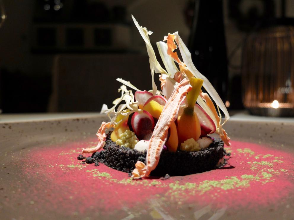 PhotogalleryOur dinner at Stube Gourmet, depicted by Tanio Liotta. We start with Duck breast, pumpkin mostarda, sesame wafer and tarragon 
Savoury cone with veal steak tartare, marjoram and salmon roe
A reconstructed tomato: mousse of tomato, vegetal carbon, mousse of almonds, basil gel
Fake peanut with foie gras, cocoa butter, horn of plenty 
Excellent bread and butter
