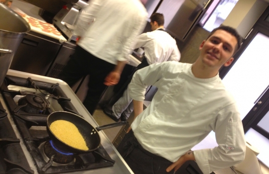 Photogallery






 
Modena’s colonnades, 186 thousand inhabitants and 3 restaurants with at least one Michelin star: Hostaria del Mare (1), Erba del Re (1) and Osteria Francescana (3 stars), our destination
 








Yellow and red tones prevail








The city still bears the signs of the May 2012 earthquake. On May 4th 2013, the day of our visit, a 3.8 magnitude earthquake was registered













By chance, Giuseppe Palmieri, maître and sommelier, appears from the grey door








Palmieri, 38, born in Matera. His first service in Francescana was on September 12th 2000








The old entrance to the restaurant, at number 24 in Via della Stella - as on the opening in 1995. It changed in September 2012: today you enter from number 22. Funnily enough, Google Maps is still set on the old entrance








The present entrance doors








Let’s start








After the latest renovations, the transit areas inside the Osteria appear as a contemporary art gallery








Mario Schifano’s world map








"Tourists", Maurizio Cattelan’s famous pigeons








Underneath the pigeons, Gavin Turk’s “Trashbag”








Three rooms, 12 tables, between 20 to 35 guests. 40% guests are Italian








Every table is illuminated by Davide Groppi’s Sampei lamp: if tables are moved, light follows








Francescana receives 150 reservations every day. But it also suffers from clients not showing up: on average, one table every week is booked but then guests don’t come








Right behind the kitchen, there’s the prêt-à-porter cellar








"In the central cellar, we only keep great vintages and larger bottles of what we consider to be great wines", Beppe Palmieri explains








1,600 wines are listed at Osteria Francescana, with a deep wine list which includes different vintages of the same wine








"A true celebration of wine "








The Ferrari coat, hanging in the cellar: Maranello is only 17 km away from Modena








Jean Todt, Michael Schumacher, Fernando Alonso: Ferrari’s “prancing horse” is at home in Via Stella








Gabrio Bini’s wines, from Pantelleria, a real fetish for Palmieri













Hanging from the ceiling, a nice selection of cured meats from Emilia








Bread made with mother yeast, the premise to a journey which will alternate great classics with very contemporary dishes








Massimo Bottura. Fifty years old last September, he is chef since 1986, the year of Trattoria del Campazzo in Nonantola. His first masters: Lidia Cristoni and Georges Cogny








He’s glowing: a few days ago his restaurant climbed, for the first time, onto the podium of the World's 50Best, a prize that is acquiring an increasing weight and authority. "The thing that makes me the happiest", he says, "is not so much the third place, but the fact that we’ve been in the highest positions for a few years now". True: 13th in 2009, 6th in 2010, 4th in 2011, 5th in 2012, 3rd in 2013








The now famous grey New Balance 993, a real emblem for the chef, friend of Jason Weis, president of the company in Massachusetts. The insole, however, is local: "In Emilia the sector is state-of-the-art", he says








"Are we ready?"








Almond granita with capers, bergamot and coffee cream 
Bottura and Palmieri’s journey across Italy starts from the bottom. And sails off from the Sicilian inland, with a classic granita which in Modena crumbles Adria-style, the wall that divides sweet from savoury, using the picklock of bitterness: Pantelleria capers, wild oregano but also bergamot, a coffee concentrate and vanilla scented salt. To pair with the first part of the meal, Sorriso di Cielo malvasia dei colli piacentini








Mediterranean Macaroon 
Next to the granita, two peculiar macaroons: the first is made with minced anchovies and sardines, the second with oysters and seaweeds. This is a classic scheme in Bottura’scuisine: his ironic turning the order of the dishes, from starter to dessert, upside down, and using popular raw materials instead of ingredients that are emblematic of élite cuisine. «While feet are sinking in the ground, the head is free to move everywhere», is one of his most famous quotes








Tempura of freshwater aulla with carpione ice-cream
Carpione ice-cream on a tempura of freshwater aulla – these fish are similar and slightly bigger than whitebait. The tempura is made by quickly placing the cold batter in boiling oil








Bread and croissants








Grissini








Baccalà Mare Nostrum 
We move up the Tyrrhenian sea to find this salted codfish cooked at low temperature and then seasoned with a touch of Naples and the Amalfi coast, that is to say with an emulsion made with hot oil with tomato vegetal liquid, olives, the zest of Sorrento’s super lemons and some anchovy colatura. These aromas crack with the scented bread on top








40 year old Denis Bretta explains the dishes as if from a book. Once at Restaurant Fini in Modena, for the past year and a half he’s been the manager responsible for the service in the restaurant. But don’t ask Palmieri to explain his role, as he’s abolished all hierarchies: "In our restaurant there are no commis or chef de rang. At a time when titles are so abused, I prefer for us to be all colleagues. All waiters."








How to burn sardines in three days 
Another journey, another horizon, the Adriatic Sea between Romagna and Ancona. A new camouflaged expression: these are not sardines (and they aren’t burnt either) but they are small sea-rock mullet, marinated for 3 days, then seared on one side on a grill, and filled like a sandwich with some (very sweet) scampi cream, and covered with vegetable ashes, aromatic herbs and lemon zest. “I wanted to make fun of the Marche-Romagna habit of grilling everything”, the chef says, “with lemon, garlic and parsley always added later to fix everything”









Rice, between fresh and sea water 
Recalling the Po estuary with freshwater and brackish sensations. The freshwater flavours cover the surface of the oyster which prevails on the river bed. And in the end, catfish, carp, vegetable chlorophyll and carpione win once again








 
A journey to Modena: Adriatic eel, polenta, Campanine apple jelly and saba
Another fluvial odyssey, presented for the first time at Identità Milano in 2011. The Adriatic eel travels across Veneto (with the polenta cream), Mantua (the Campanine apple jelly), the countryside of Modena (with the Saba lacquering, that is to say the mother of Aceto Balsamico) and stops in the centre of Modena (blackened powdered onion, a mimesis of the town’s canals)
 








Normandy
That is to say pre-salè lamb (hanging for 20 days) with an emulsion of oyster water, fresh seaweeds and caviar. On top, a green apple granita that recalls cider. “This is our tribute to Normandy”, Bretta says, “in Modena there are no enchanted beaches or breath-taking mountain tops. From Via Stella you can’t even see the Torre Ghirlandina. What guides us is the persistant strength of ideas, woven into the culture and into memories”








Giovanni Boroni’s Genziana from Trentino. A brilliant idea by Palmieri that acts as a bridge between the two dishes, Normandy (previous picture) and Think Green (next one). This distillate plays an immediate contrast with the sea-character of the first dish: "To me, harmony is what is left after a confrontation", B.P. says. And the confrontation is followed by the thought that spurs from the following match: water is added to the Genziana and the palate surprisingly longs to gulp it all. This is the perfect vehicle for the aromas of the genziana and "gives length" to the minerality of the wild herbs. "This serves to recall water, our true source of richness". Brilliant








Think Green
Vegetal chlorophyll, asparagus tops, pea cream, mushrooms, truffle, flowers, aromatic herbs and Parmigiano Reggiano curd. The idea of this dish came after observing the biological cycle of grazing cows, 4 seasons that sum up all of life. “This is what the cow eats, and what it returns to us, thanks to an extraordinary milk”, Bottura adds








Five ages of Parmigiano Reggiano 
A great classic from 1996, "when the textures in fact were 3", Palmieri points out. Today they are 5: 4 month ageing cream, 30 month demi-soufflè, 36 month mousse, 40 month crispy wafer, on top, “air” of 50 month Parmesan. (photo by Le Saucier)








A compression of pasta and beans 
Another great classic, this is a journey across Bottura’s experiences in the kitchen: Creme royal with pork rind, beans and foie gras (French tradition), rosemary air (the Spanish vanguard) and Parmesan crust (the Emilian essence) used instead of pasta. “This is a dish based on evolution, not revolution. I compressed my grandmother between Alain Ducasse and Ferran Adrià”








Snails under the grapevines 
Snails, aromatic chlorophyll on a bed of wild vegetables and herbs, with mushrooms, truffle and bulbs. After the cow’s life cycle, here comes that of the snail. "Once again, we’re chewing the territory: the best snails slither in the vineyards, among mineral, sapid and acid aromas"








A Frenchman’s dream of making pasta like an Italian 
Or, Ravioli with leeks, foie gras and truffle. We covered this in detail in Identità di Pasta issue number 27








Damijan Podversic’s Ribolla Gialla, a great wine by a wine producer from Gorizia inspired by Josko Gravner. It will support the following dish, without concealing it








A sharp knife is only served now. Another sign of the “allergy” to lengthy chewing that characterises most of contemporary high cuisine








Pigeon hunt 
And over to Bretta: "This is served in a balsamic sauce made with beetroots, which recalls blood. The salad is made with fake leaves, made by cutting out some tubers using some small stamps. These are then compressed in a vacuum with different types of vinegar. The horseradish is grated a few seconds before service, to give some velocity to the pigeon". Irony wins, since "pigeons are not hunted". The bird supplier is Franco Cazzamali from Cremona








Before the dessert, a trip to the restroom: vegetal notes prevail here too








A visit to the kitchen: capon stock








The chef watches over everything, even on the loud music wired wireless from the ceiling. When we get inside, Rod Stewart is screaming "Do you think I'm sexy?"








Meanwhile, the sauces are prepared for the evening service. There’s no break between lunch and dinner. "People sometimes leave at 5 pm because they come here to enjoy the experience of a lifetime", Palmieri reveals, "We work non-stop and every year is worse (or better, that is to say). Don’t ask me anything after midnight, though, because I can’t think straight"








Between dining room and kitchen, today 27 people work at Osteria Francescana. Many of them are interns: "Had I been offered an internship with Ducasse, at the time”, Bottura says, "I would have paid myself". In fact, he really took an internship at the Louis XV in Monte Carlo, in 1992








Leaves 
The journey takes us amidst the forests beds in Umbria: the real leaves change according to the season (black cabbage in winter, red and green basil in spring), they are caramelised and then worked with some chestnut and hazelnut paste, with a vin brulée reduction, chocolate and citrus fruits concentrate...








Magnum of Foie gras (before)
A foie gras terrine, vacuum cooked, covered with powdered toasted hazelnuts and chopped toasted almonds, finished with some apple Balsamic Vinegar. This is possibly Massimo Bottura’s most famous (and copied) dish. Alessandra Meldolesi, in her book "Sei. Autirotratto della cucina italiana d'avanguardia" she writes: "It’s a trompe-l’oeil starter in which a mould unmistakably used in the food industry, encloses the secret of the most exclusive delicacies, foie gras and Aceto Balsamico Tradizionale. This is snack versus high cuisine, dessert versus starter, entremets versus carne: the triple antiphrasis manages to get a smile"








Magnum of Foie Gras (after)
Ehm








Oops, a broken lemon tart 
A lemon tart with lemon zabaglione, lemongrass ice-cream, lemon confit, capers and bergamot (with the latter, we go back to where we had started from). This is the last dish of a masterly journey








Sous chef
Here are the staff. We start with Yoji Tokuyoshi, 35, from Japan, for 8 years at Osteria Francescana. He’s just back from the Postrivoro for Slow Fish








Managing orders
Takahiko Kondo, from Japan








Starters
Davide Di Fabio, 27 from Abruzzo








First courses
Michele Castelli, 28, Matera, in Modena since 5 years ago








Main courses
Riccardo Forapani, 27, from Cavezzo (Modena) at Osteria Francescana for the past 5 years and a half








Pastry Making
To the right, pastry-chef Alberto Buratti, 26 from Legnano (Milano), ex Antica Osteria del Ponte with Ezio Santin. With him, Matteo Conterio, from Como, 20 years old, Francescana since last month





