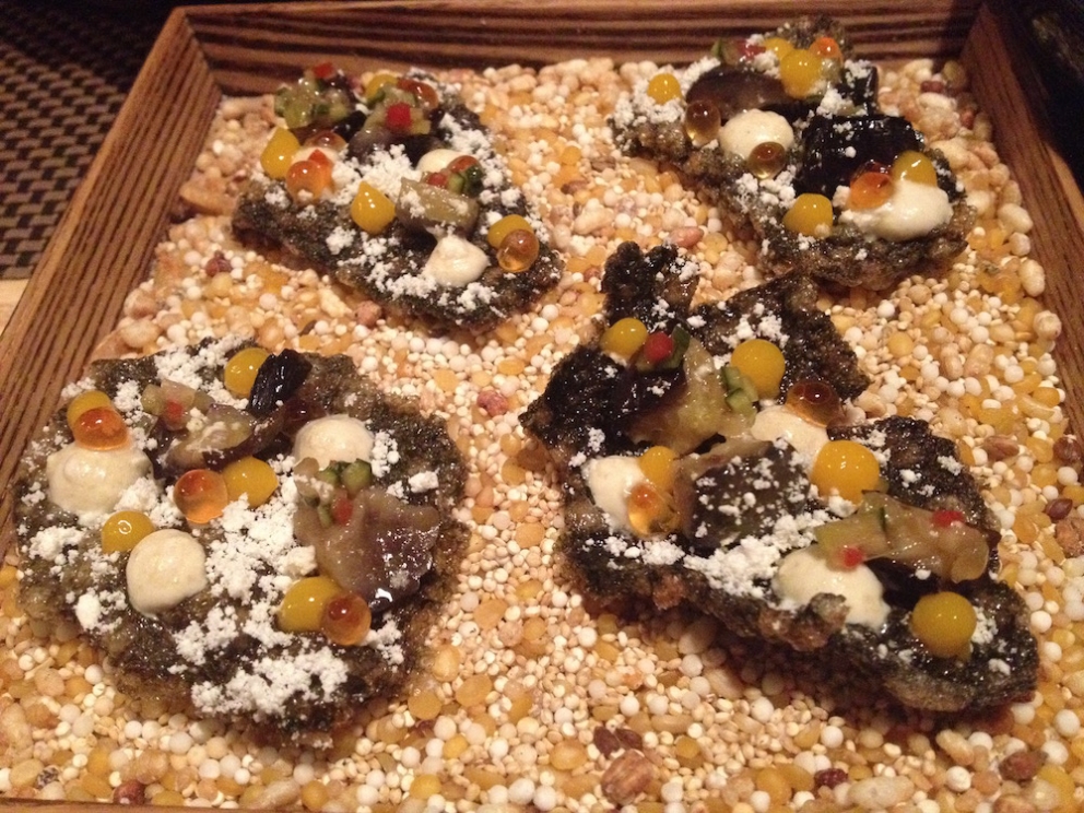 Galleria fotografica






Panoramica dal 32mo piano del Lotte Hotel di Seul. La capitale della Corea del Sud (che i locali pronunciano "sol"), con 10 milioni di abitanti (25 considerando tutta la proncia di Gyeonggi) è tra le città più popolose al mondo








Sfigurata nel Novecento dai Giapponesi (prima parte del secolo) e dalla guerra di Corea (1950-1953), oggi Seul ha un aspetto moderno, piuttosto occidentale








Con decine di milioni di turisti all'anno, Seul è tra le 10 città più visitate al mondo. Nella foto, una delle attrazioni più viste in città: il Dongdaemun Design Plaza, progettato da Zaha Adid e Samoo e completato nel marzo del 2014
 








A passeggio per il quartiere di Myeongdong, molto frequentato anche per l’alta concentrazione di ristoranti








Il viaggio era cominciato bene: tra le opzioni commestibili sui voli di Korean Air c’è proprio una squisita Bibimpap, con tanto di foglietto illustrativo








Bancarelle all’ingresso del mercato Namdaemun, tra i più popolari di Seul. Chiunque può andare e comprare; non occorrono licenze








Namdaemun, trippa a mollo








L’affitto di una bancarella al Namdaemun costa circa 2.000 dollari americani al mese, ma consente un ricavo medio mensile di almeno il doppio








Cozze giganti, molto popolari sulle tavole coreane








I mercati sono sterminati, molto puliti e per nulla caotici








All’interno del mercato, c’è anche un ristorante molto spartano e molto buono. Serve di tutto: hoe (pesce crudo), kimchi (verdure fermentate), guk tang (zuppe), bibimpap…








Baek kimchi: cavolo stufato con rape bianche, pere, prezzemolo coreano. Talvolta è servito anche con le castagne








Scodella di Bibimbap








Uova di quaglia bollite, aglio e edamame








A chiusura del pasto, ecco una bella zuppa fumante (erano le 8 del mattino)








Zuppa di alghe e merluzzo








Mingles, sulla Cheongdam-dong nel quartiere di Gangnam-gu, è l’indirizzo più interessante di cucina coreana contemporanea. L’ha aperto poco più di un anno fa Mingoo Kang, tornato a casa dopo esperienze da Martin Berasategui e da Nobu Bahamas








Mingoo Kang propone un solo menu degustazione da 88.000 won (circa 70 euro). Ognuno dei piatti contiene sempre un elemento fermentato








Mingles esprime un approccio creativo fondato però sulle salse fermentate, pilastro della cucina coreana tradizionale: cho (aceto), gan-jang (salsa di soia), gochu-jang (pasta molto piccante di peperoni rossi, fagioli di soia bolliti e sale), doen-jang (pasta di fagioli di soia), erbe e spezie








Composizione iniziale di amuse bouche. Da sinistra a destra: Polpo, foglia di senape e pasta di aioli fermentata; Gelatina di bacche omija, zuppetta di asparagi bianchi, mirtilli e spuma di aceto nero e Pera arrotolata nella sogliola (salsa di gochu jang marinata nello yuzu), uva e peperoncino








Sandwich di fegato di rana pescatrice in sfoglia di miele su chip di funghi








Insalata di noodle di riso con senape coreana, spuma di tofu, alghe marinate, abalone e aragosta








Torchon di foie gras marinato nel doen jang (pasta di fagioli di soia), vino di prugne dorate corane e kimchi bianco








Branzino al vapore con calamari mignon brasati in cima e alga combu, brodo di alghe, granchio e kimchi bianco





