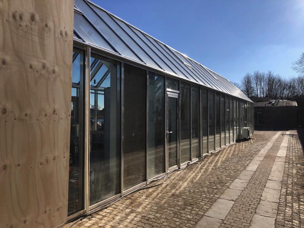 Photogallery






Noma 2.0 is in Christianshavn, the same neighbourhood as the first Noma. They’re 1.5 km apart, a 15 minutes’ walk. This picture shows the distance: to the right, there’s the warehouse of the old location (in Strandgade 93), to the left the smokestacks of Amager Bakke, the futuristic incinerator below which stands the new Noma (in Refshalevej 96)









Weather permitting, you can have a peaceful walk between the previous Noma to today’s Noma 









The new Noma is on an isthmus surrounded by canals. In the future they also want to reclaim some small parts for hydroponic farming









Bucolic scene with incinerator









Bikes left outside Noma. It’s the favourite means of transport among employees and interns









The long path taking you to the restaurant. The fence on the left shows how works are still in progress









On the two sides of the path there are the two new sections of the "Noma village", each with its specialty: grill, hot dishes, snacks, fermentations... In one month’s time, behind the fence we’ll have greenhouses, the test kitchen and the bread making area






