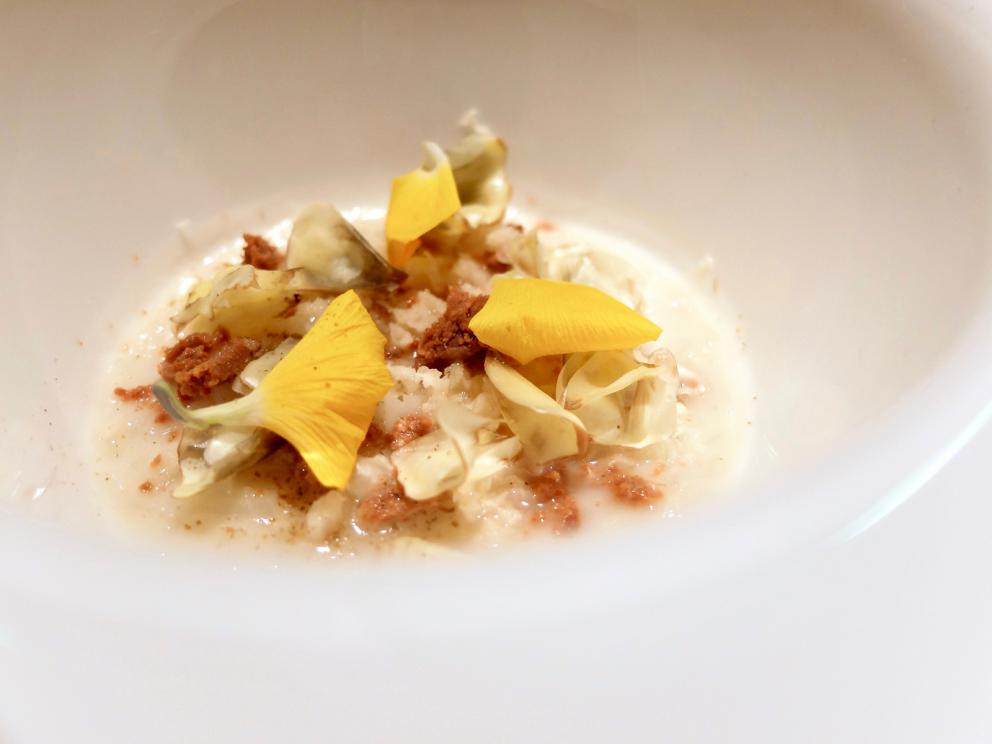 Photogallery






A new Lorenzo Cogo at the new El Coq, since July 2016 in the heart of Vicenza









At the entrance, the Carlton library by Ettore Sottsass, a great designer, founder of the  Memphis Group. In fact, it is entirely made in sugar, the work of artist Marco Chiurato

 









We get to the first floor: the perspective at the entrance recalls the depth of Palladio’s works









The elegant dining room









Precious cutlery by Giò Ponti for Sambonet. Everything is studied: the colour of the tablecloth is inspired by the roof of the Basilica Palladiana









The view from the dining room...









...and from the kitchen









Let’s start: Cherry tomato, angustura, vegetable jus. All the photos of the dishes are by Tanio Liotta









Beetroot macaroons with radicchio and Béarnaise sauce with mint 









Choux pastry with peanut cream and dried bacon 









Doughnut with goat cheese and curry cream: the last appetizer









Fondale marino, scalogno, salmone e salicornia: the shallot is chargrilled, there’s peppermint mousse, powdered salmon, and granita made with sea asparagus and orange bitter









Amberjack belly, rosola and peas: an improvisation based on what was available from the market. Fish and peas are chargrilled, then there’s a vinaigrette of pods and rosole, poppies









Chargrilled calamari, babaganush, bergamot and teriaki: the grill, once again. Cogo learnt its perfect use from Basque master Victor Arguinzoniz of Asador Etxebarri

 









Bosaga roe, yellow pepper, sake and ice camomile. Masterful what with complexity and elegance. Bosaga is a fish typical of Chioggia






