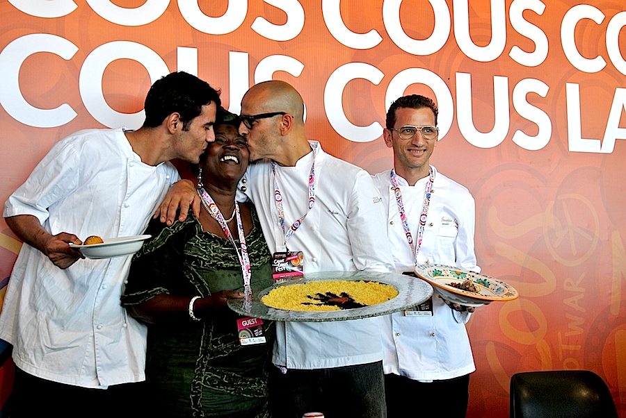 Galleria fotograficaIl cannolo di cous cous di Enrico Panero, del ristorante Da Vinci a Eataly Firenze, usato come evidenziatorePrima nazione in gara al Cous Cous Fest 2014 il Marocco con Majda Nabaoui, cuoca 19enne in forza all'Osteria Francescana a ModenaMajda Nabaoui, in Italia, a Modena, dall'et&agrave; di 9 anni, ha chiamato la sua proposta Da Modena al Marocco passando per la Sicilia, la sua colazione la mattina di sabatoI due concorrenti della Tunisia, entrambi in forza al Taglio a Milano, a destra Domenico della Salandra e al centro Mohamed Mabrouk catturato dalla bellezza della presentatrice Eliana ChiavettaL'Arancino di cous cous grazie al quale la Tunisia &egrave; arrivata alla finale a livello di giuria popolare superando il Marocco per appena un centesimo: 8,92 contro 8,91. Al suo interno scampi freschi. Nota curiosa: visto che eravano nel Trapanese, quindi Sicilia occidentale, sarebbe stato pi&ugrave; corretto chiamare il piatto ArancinaTre giorni di assaggi, tutto nel PalaBia, il tendone ridosso della spiaggia di San Vito Lo Capo. Il cielo ti invitava a mollare tutto e a tuffartiIl Cous Cous dolce, nome concreto del piatto della Francia, delle cuoche Marion Roger (cous chef di Alice Delcourt all'Erba Brusca a Milano) e Chiara Cilio, che hanno proposto un uso insolito del cous cous, in forma dolce, con tanto di gelato alla verbena. Con questo dessert, la Roger ha vinto il premio per l'originalit&agrave; e sfiorato il successo assoluto, centrato dalla Delcourt nel 2011 e 2012Maziar Farivar, radici iraniane e cittadinanza statunitense. Del suo piatto ricorderemo solo un eccessivo e gratuito uso del peperoncino. Doveva essere un cous cous nel segno dello Shrimp Jambalya ma, eliminato il prosciutto affumicato nel timore di imbattersi in musulmani in giuria, tutto &egrave; crollato.Il cous cous americano, un piatto imbarazzante, facile preferirgli quello francese. La giuria popolare ha votato il dessert 8,86 e il cous cous patriottico 7,86 (ma la giuria di esperti &egrave; stata ancora pi&ugrave; severa)Mohamed Mabrouk e Domenico della Salandra per una volta schierati nella giuria popolareIsraele in gara contro il Libano grazie a Michael Korenman, tutti presi in contropiede perch&eacute; si aspettavano un Michele, un lui e non una leiMichael Korenman &egrave; stata anche la cuica personale di Oprah Winfrey in America, conduttrice tiv&ugrave; e attrice. Il suo cous cous &egrave; piaciuto pi&ugrave; agli esperti che al pubblico. Ricco di spunti come i falafel, ottimi i singoli pezzi meno l'assemblaggio finale e un attimo inutile il tonno come nota del mare. Il piatto non aveva un nome: "Abbiamo avuto un'estata difficile per via della guerra che proprio non avevo pensato a come chiamarlo. Lo faccio ora e lo chiamo PACE". Applausi scrosciantiNahida Salman, cuoca libanese che dal 2006 vive a Ragusa in Sicilia, tra i suoi parenti anche l'attuale presidente della Repubblica del Libano Michel Suleiman. Il suo cous cous, lo Yakneh Tabule alla carne di agnello, &egrave; stato preferito per due centesimi dalla giuria popolare: 8,57 contro 8,55.Un dettaglio del cous cous libanese, il tabul&egrave; usato dalla chef come ripieno degli involtini di foglie di viteCome per Israele, la partecipazione dei cuochi della Palestina assume sempre un significato che trascende quello gastronomico. A volte ci scappa pure un signor piatto, non &egrave; stata questa la volta ma Hani Kasabra e Odeh Abu El Hawa hanno lo stesso strappato applausi. Se &egrave; stata un'estate pesante per chi vive in Israele, figuriamoci per loro (che, comunque, non arrivano da Gaza bensi da Betlemme). Sono ampiamente scusati se non hanno versato il miele in un cous cous di pollo e verdure in brodo, miele annunciato nel nome stesso della preparazione.Il Cous Cous con pollo e verdure della Palestina. Tanta buona volont&agrave;.Mamma Africa alias Konate Abibata, nativa di Abidjian e a Palermo dal 1994 dove presto avrebbe aperto un'osteria nel quartiere di Santa Chiara per i suoi connazionali ivoriani e via via per sempre pi&ugrave; italiani. Gi&agrave; nonna di sette nipoti, anima una fondazione a favore dei bambini del Burkina Faso, "un Paese ancora pi&ugrave; povero della Costa d'Avorio". Vincitrice due volte del Cous Cous Fest, 2006 e 2008, superata la Palestina per 9,11 contro 8,24, Mamma Africa si &egrave; aggiudicata il premio per la migliore presentazione.Mamma Africa ha chimato il suo cous cous Gli spiedini della nonna, lei ormai nonna e molto attaccata a sua madre. Per&ograve; gli spiedini di manzo non hanno sfilato. La cuoca ivoriana ha usato l'occasione per lanciare un messaggio di pace e di fratellanza tra le nazioni di Africa (la mano nera) e Europa (il fondo bianco) nel segno di un cuoro rosso e vivo. Il cous cous della Costa d'Avorio come &egrave; stato servito alla giuria tencica. Particolarmente scomodo e brutto il bicchiere per il sugo di carne, ma molto funzionale alla riuscita del piatto perch&eacute; uno poteva versarlo subito prima di papparselo. In finale invece Mamma Africa ha preferito, in assenza di bricchetti, versare il sugo prima di servire, ma cos&igrave; il torrino &egrave; risultato asciutto.L'ultimo confronto eliminatorio ha visto in gara l'Italia e l'Eritrea. Primi a uscire in sala i cuochi azzurri, il sanvitese Giuseppe Salmeri, in forza all'hotel Capo San Vito, tutto a sinistra nella foto, e il milanese Andrea Provenzani, chef-patron del Liberty.Andrea Provenzani aveva vinto le selezioni di giugno per rappresentare l'Italia al Cous Cous Fest vero e proprio, assieme con Giuseppe Salmeri, grazie a un piatto dominato dal pesce spada. Tre mesi dopo la ricciola, un esemplare di 36 chili, ha preso il posto dello spada e il piatto, presentato come La mia Sicilia, &egrave; diventato La nostra Sicilia, di Andrea e di Giuseppe. A fine eleminatorie, &egrave; risultato il pi&ugrave; voitato: 9,44. A farne le spese l'Eritrea, voto 8,58.Al cous cous italiano, per essere gustato, mancava il tocco finale, un latte di mandorle naturale, preparato dagli stessi chef.Neil Vivaldo, classe 1974, inizi&ograve; a lavorare nel ristorante eritreo dei genitori a Torino, il Mar Rosso, quando aveva 22 anni. Era il 1996 e solo da poche stagioni ha lasciato la sala per la cucina. A San Vito Lo Capo si &egrave; presentato con la madre, Harig&ugrave; Tealwe, brava a confezionare un Cous cous all'abissina.Il Cous cous all'abissina di Neil Vivaldo e sua madre Harig&ugrave; Tealwe. Per l'abbondanza di frutti di mare e crostacei nel sugo, &egrave; stato ribattezzato Cous cous allo scoglio.Fiamma Luzzati, una disegnatrice italiana di radici siciliane che da tempo vive a Parigi. Prezioso il suo contributo in giuria.