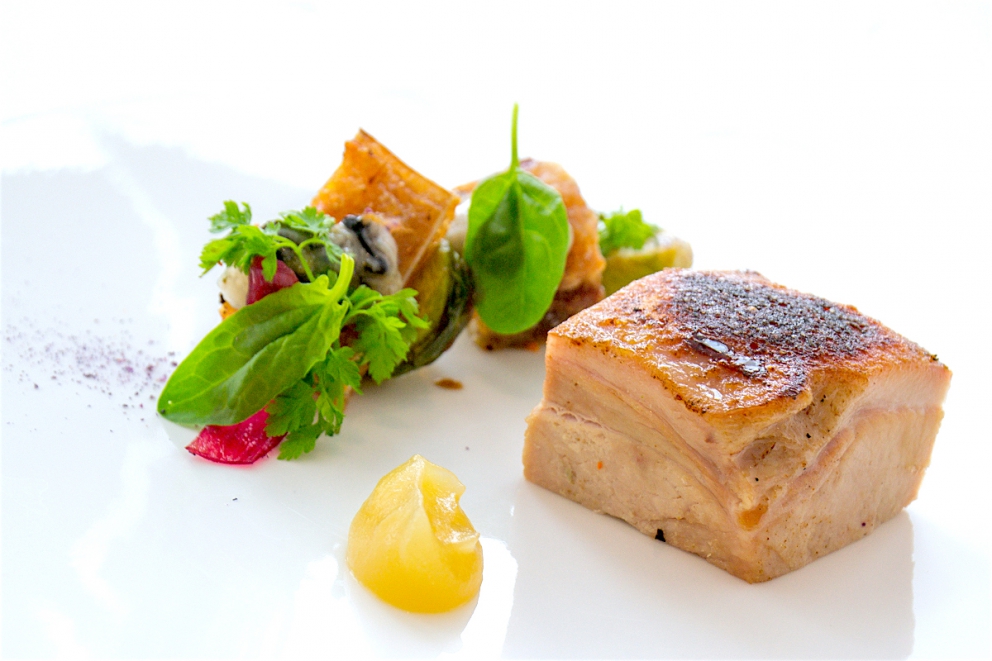 Photogallery






Enrico Crippa, Piazza Duomo, Alba (Cuneo)

Prawn and radicchio from Treviso cocktail – It’s a take on prawn cocktail with radicchio from Treviso first vacuum cooked and then opened as if it were a water lily. The prawn is seasoned with smoked pancetta cooking water. Then prawn bisque and a drop of shiso vinegar. Hence the classic dish acquires a new dimension, seasoned with choron sauce, which is basically a Béarnaise sauce with tomato









Andrea Ribaldone, I Due Buoi, Alessandria

Fassone beef agnolotti – Subtitle: “Memories of a trip to Japan”. Because I unite a true Piedmontese classic with a typical Japanese technique, soba in ice. Hence: cold agnolotti, in ice, with the intensity of the stuffing enhanced by the low temperature. I connect with the territory: not having agnolotti in the menu, in Piedmont, is blasphemy. However, I present them almost crispy. I took the recipe from my aunt, from Lu Monferrato, and remembered when as a child I would eat her agnolotti as soon as she made them, still raw and callous









Riccardo Aiachini, La Fermata, Alessandria

Chicken alla Marengo... – It’s an ancient recipe dedicated to Napoleon after the battle he won against the Austrians in June of 1800. With a contemporary take, of course









Davide Palluda, All’Enoteca, Canale (Cuneo)

Salted codf with milk and onion caramel – A veil of pungent and sweet caramel, with dried onion amplifying its flavour, on top of the salted cod cooked with milk. A sumptuous and intrigating dish, with white and milky tones, connected with my past and the history of many regions that don’t have any sea but have always been dreaming of it when cooking









Marc Lanteri, Al Castello di Grinzane, Grinzane Cavour (Cuneo)

Marco Martini’s Fassone steak tartare, light whole grain mustard mayonnaise and Parmigiano matured 30 months – This dish is a classic from the Langhe, to which I give a touch of France thanks to the light whole grain mustard mayonnaise









Barbara Scabin, Blupum, Ivrea (Torino)

L'isola galleggiante dei cugini d'Oltralpe rivisto al contrario [The floating island of the cousins from the other side of the Alps, seen upside down] – Quoting Wikipedia: it’s a relatively light and moderately sweet dessert, so much so that if prepared with the necessary attention, it can also be eaten by people suffering from diabetes, cardiac and celiac diseases









Marco Rossi, La Mugnaia, Ivrea (Torino)

Testacoda – These are cheeks cooked very slowly, tail wrapped in cabbage and fillet tataki with horseradish. In other ways, it’s Piedmontese fassone from the Langhe to Japan…









Marta Grassi, Tantris, Novara

Prospettiva nord: baccalà e culatello s’incontrano [Looking North, salted cod and culatello meet] – Two elements, two Northern regions, the former sober and simple, the latter opulent, meet and melt









Antonino Cannavacciuolo, Villa Crespi, Orta San Giulio (Novara)

Prawns, egg and tomato – My personal play with marine textures. This fake mini sunny side up egg is my south with earthly aromas such as tomato and inside a tartare of raw prawns. Red prawn from Sicily is still one of my favourite crustaceans, it’s a part of my life (photo credits Viaggiatore Gourmet)









Christian Milone, Trattoria Zappatori, Pinerolo (Torino)

Egg and eggs – Egg yolk with truffle, caviar, celery broth and parsley buttons... with herbs. There’s a world inside, it pulls down prejudgements and popular beliefs having everyone’s taste agree









Christian Meloni Delrio, Casa Baladin, Piozzo (Cuneo)

A cage made with quinoa, scampi and burrata – A simple yet flavourful dish, perfectly matched with our Wayan beer, a saison with scents of pepper









Davide Scabin, Combal.zero, Rivoli (Torino)

Saltimbocca alla Combal.zero – When you see a slice of prosciutto and some sage on top of a slice of meat you know it’s a "saltimbocca alla romana”. As of today, when you see a slice of prosciutto and some sage on a pasta lasagna (the egg-pasta must be at least 4 mm thick), you’ll know it’s a “saltimbocca alla Scabinsky”. The only variation: 3 different prosciuttos are used, one from Piedmont, one from Parma and one from Tuscany (from the great Fracassi)









Igor Macchia, La Credenza, San Mauro Torinese (Torino)

Felicetti Conchiglioni with squid ink, mussels, potatoes, chicory and candied ginger – All the flavour of Italian tradition plus the lightness of the Japanese one









Luca Zecchin, Guido da Costigliole, Santo Stefano Belbo (Cuneo)

Steamed and then roasted duck thigh with Abate pears, honey and pepper from Val di Maggia – A dish that encloses our tradition and connects our borders in Italy









Ugo Alciati, Guido, Serralunga d'Alba

Cardoons pears and anchovies – An unusual and intriguing pairing, the meeting of three Piedmontese ingredients that aren’t normally matched: hunchback cardoons from Nizza Monferrato, Madernassa pear and salted anchovy









Massimiliano Musso, Cà Vittoria, Tigliole d’Asti (Asti)

Rabbit, artichokes, liquorice and vegetal notes – I’m proud of this dish because in Piedmontese tradition roasted rabbit is always present in the Sunday lunch menu. I enriched it with a modern cooking technique (that is to say low temperature), pairing it with artichokes cooked in a vacuum with oil aromatised with toasted and blended peels and a liquorice mayo. Finally herbs, a vegetal touch coming from my kitchen garden









Claudio Vicina, Casa Vicina a Eataly, Torino

Kabuki 2013 – From 2013 onwards, it has undergone many changes. It’s a complete main course in terms of nutrients and calories. It was born as a starter in ancient times (tartrà). It then became more refined, in the shape of a pie, and today it’s a complete vegetarian dish. It’s called Kabuki because of it’s an explosion of colours, vegetables (4 or 5) and flavour. We serve it thus: a pie made with courgettes and Grana Padano matured 24 months in the centre of the dish. Finally, on top of the pie, we carefully put the egg yolk breaded with brioche crumbles fried in extra virgin olive oil









Matteo Baronetto, Del Cambio, Torino

Lasagne with sea lettuce and veal meat sauce (without tomato) – The sea lettuce lasagne is an almost natural and spontaneous version of Gualtiero Marches’s lasagne made with green pasta and pheasant meat sauce which I made again and again. It is natural and spontaneous in that the idea is not of giving a new take on the classic lasagne but a chance to a celiac to taste the primary taste of lasagne. The sea lettuce in fact shows no difference with the classic Italian green coloured pasta









Marcello Trentini, Magorabin, Torino

Puntarelle/Burrata/Anchovies- A delicious and complex snack uniting North and South... Hanging in the balance between bitter, sapid, sweet and umami






