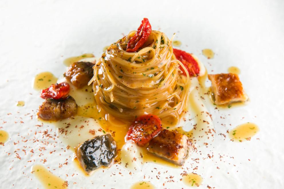 Photogallery






Together with the celebration, the report of a recent dinner at Imago inside hotel Hassler, with chef Francesco Apreda, much appreciated at Identità both professionally and as a person. As we said on the Guida Identità Golose 2017, "if you think about it, it’s a nice paradox: in the Eternal City, from the 6th floor of hotel Hassler, there’s a talented chef from Campania who makes you travel around the world for a few hours. There’s enough to make you forget the stereotype according to which Rome is so full of history it’s just concentrated on itself, and thus provincial". (Carlo Passera)









We start with Celeriac, peppers and ginger; Daikon with yuzu and black truffle; Radish with lime and gin: all in osmosis. There’s technique at the service of the creative mind, resulting in a debut that prepares the palate whetting the appetite. Followed by Egg in tempura, lime and fig mustard: delicious without trying hard to please









Foie gras and scones, Sweet Rain blend (2015): this, like most of the dishes by Apreda, is characterised by the blend of spices that originate from the chef’s long experience around the world (see also: I Sapori di Viaggio di Apreda). It was part of the "menu 10 anni"









Apreda with his blends. As we mentioned, the chef "interacts with the client, mixes territories and stories, draws from his experience in every continent and sums this up in spicy inspiration: he may add Napoli, Mumbai, and so on (he studied and defined a total of six aromas, each with a precise geographic origin: so it’s enough to add a pinch of London or New York. Your taste buds will be thankful "). The next dish, among the new ones in the menu, is truly fantastic: Seafood vegetable minestrone. One of the best, in a tasting menu that always has the highest quality. In this case potatoes, onion, celery, baby spinach, leek and parmigiano wafer meet a seafood broth made with kombu seaweed









Mozzarella di bufala INConsistenza, scapece di appiccatelli vesuviani, another voluptuous dish in the menu. Different textures of mozzarella (as a film, dehydrated, in a mousse, a sauce, in pieces, in gel...) with a pinch of Napoli, yet in the sense of a mix of herbs recalling the city









Scallop shabu in a carpaccio, yuzu and black truffle, turning upside down the litany of a mollusc often overused in fine dining, making its taste once again interesting. The photo, however, is of the Breaded scallops, shitake and black truffle, from 2007, in the anniversary menu: the same applies. The scallops filled with buffalo milk mozzarella, truffle and celery leaves had a different breading, instead of the classic Milanese style (breadcrumbs and flour) there’s now panko (Japanese breadcrumbs) and dry Indian rice flakes, while the sauce is made richer with shitake mushrooms: the dish, thus assembled, is served with a broth on the side, so as to enhance its textures. This is also Roberto E. Wirth’s favourite dish









Octopus and seaweeds, roots and Uma-Mia blend (2016): as in the case of the scallops, Apreda is never banal









The starters finish with a Tartare of prawns and veal tongue, puntarelle and ponzu









This is a great classic of the chef, deservingly celebrated: Cappellotti Double Umami (Blend Spicy Bomba-y). A contrast of temperatures: the filling of the pasta, made with parmigiano and katsuobushi, is hot, while the broth, made with tuna and double malt beer is cold. Trenette with shiso pesto, squilla mantis and potatoes and Risotto with red onion and foie gras, spicy powdered coffee, two new dishes









In the anniversary menu, there was a different risotto: Risotto cacio pepi e sesami, from 2012 (he added pecorino water, made by blending pecorino in hot water, then placing the mixture in the fridge: the fat solidifies on top, the proteins fall below while in the centre there’s the water in which they cook the risotto)...






