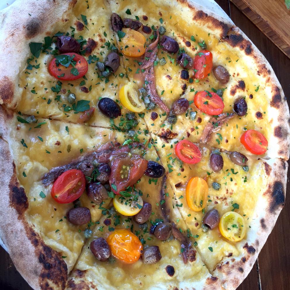 Galleria fotografica






Con l'aereo che sarebbe atterrato all'aeroporto di Melbourne alle 4.20 del mattino di martedì 4 aprile, ha fatto davvero piacere entrare della stanza 1729 del Langham Hotel lungo la South Bank del fiume Yarra e trovarvi della frutta fresca









Lo skyline notturno di Melbourne dalla camera al Langham. Il sole sarebbe sorto un paio d'ore dopo









Prima colazione con vista sul centro di Melbourne e il corso del fiume Yarra









Nicolas Chatenier, responsabile del panel francese nella giuria dei 50 Best, ha invitato stampa, cuochi e amici al Philippe Restaurant in pieno centro di Melbourne. «La Francia e i Fifty hanno avuto in passato relazioni torbulente che stiamo superando e così eccoci qui da uno chef che ha lavorato per anni e anni con Paul Bocuse». In effetti Philippe Mouchel è quanto di più lontano possiamo aspettarci oggi da una tavola contemporanea. Da un eccesso all'altro?









Clement Vachon e Yannick Alléno









Mauro Colagreco e Massimiliano Alajmo. Per la prima volta è toccato al fratello chef rappresentare le Calandre ai 50 Best. In passato, a Londra e a New York, era sempre andato Raffaele Alajmo









Dominique Crenn, argento vivo









Una tavola italiana è sempre allegra e calamita tutti, anche Yoshihiro Narisawa









La prima cena a Melbourne? Cafè Di Stasio, la buona Italia nel mondo









Rinaldo Di Stasio, per tutti Ronnie, produce vino nella Yarra Valley dal 1994. Le etichette le cura suo padre in maniera molto singolare: scrivendo l'originale a mano



















«DOC, siamo nati pizzaioli» è scritto su una grande lavagna in una delle due pizzerie chiamate DOC da Tony Nicolini. Questa è quella in Albert Park









La stessa inquadratura di prima ma con i fattori invertiti per evidenziare la foto di papà Nicolini quando era un giovane pizzaiolo arrivato nella metropoli dello stato di Victoria









Volo di mongolfiere su Melbourne all'alba di mercoledì 5 aprile 2017









Mercoledì 5 aprile, ore 9.30 del mattino, il giorno della verità dei Fifty Best 2017: la tensione di Massimo Bottura in attesa della sera









Massimo Bottura e Ben Shewry, chef neozelandese trapiantato a Melbourne in Australia









Dan Barber, chef-patron di Blue Hill at Stone Barns poco a nord di New York. Profeta della sostenibilità a 360° ha sospirato e poi sorriso quando gli abbiamo chiesto di Donald Trump presidente: «Il mio lavoro diventa più difficile, ma la sfida molto più interessante»









A conferenza e interviste concluse, posano i 5 chef intervistati. Da sinistra verso destra Gaggan Anand, Dan Barber, Elena Arzak, Virgilio Martinez e Yannick Alléno









Foto ricordo per me con, da sinistra, Virgilio Martinez, Valeria Senigaglia, Alessandra Gesuelli, Gaggan Anand e Elisabetta Canoro









Mercoledì 5 aprile a Melbourne: alle 6.30 della sera vengono aperti gli ingressi del Royal Exhibition Building e i quasi 1000 invitati iniziano a defluire, suddivisi in due file. A destra red carpet per i vip, a sinistra il dietro le quinte per la stampa









Finiti gli scatti con mogli, fidanzate e amici, Alajmo, Bottura, Crippa e Romito, reggendo un A4 ciascuno, ricorderanno così l'amico Bob Noto, scomparso a Torino lo scorso 23 marzo. Davvero un bel gesto









All'incrocio dei due assi di un edificio che quando venne inaugurato, nel 1880, era il più grande dell'intera Australia, due grandi postazioni per il party post-premiazione. Da una parte il pesce...









E dall'altra la carne bovina. Lavorata sul posto, poi cotta alla brace all'esterno assieme a dell'ottimo agnello, la vista della mezzena di un manzo non ha entusiasmato tutti gli ospiti. Nell'alta cucina c'è anche chi è vegetariano o vegano...









Massimo Bottura e Massimiliano Alajmo ormai a giochi fatti e, soprattutto, annunciati









Tra gli espositori di cose buone durante la cerimonia anche Calia, un distributore di qualità con un miele da favola da fiori di Leatherwood, un arbusto che cresce in Tasmania. Ne ho chiesto un campione da portare con me in Italia, mi è stato dato con questa motivazione: «Lo prenda pure perché ha chiesto il permesso invece di mettersi in tasca la boccetta». In un certo senso, edificante









Il diavolo non fa i coperchi, l'iPhone non sempre fa le foto a fuoco soprattutto quando chi lo usa ha fretta di fissare un gruppo di mogli degli chef premiati come al centro Lara Gilmore, la signora Bottura









Ai fotografi professionisti le foto non vengono mai sfuocate. E se capita è perché lo volevano









Massimo Bottura non si separa mai da un tricolore che riporta i primi tre articoli della costituzione, uno per colore partendo ovviamante dal verde









Le premiazioni sono finite, la festa quasi e allora ben venga un paio di scarpe, comodissimi sandali per Ana Ros, Best Female Chef per il 2017









L'Higher Ground è un localone bello ma rumoroso accidenti, in centro a Melbourne, punto di riferimento per gli chef arrivati da tutto il mondo. Bottura e Humm vi hanno tenuto una conferenza prima della premiazione, Daniel vi è tornato con la moglie Olimpia il giorno dopo essere stato applaudito numero uno al mondo, giovedì 6 aprile









Toast e avocado all'Higher Ground per un cremoso inizio di giornata dopo una nottata in bianco per via dei 50 Best









Hummus con verdure e uovo in camicia, sempre per prima colazione all'Higher Ground









Un esterno a Carlton dove Tony Nicolini ha aperto il secondo DOC Pizza & Mozzarella Bar, 295 Drummond Street









La pizzeria di Tony Nicolini a Carlton dopo il servizio del pranzo. Nota importante: il motto di Nicolini gli fa onore: «People and pizza before profit», il cliente e il prodotto prima del profitto.









Il Grande Abruzzo in Italia e nel mondo: Tony Nicolini, ristoratore in Melbourne, e Niko Romito, da Castel di Sangro a un posto nella classifica dei World's 50 Best Restaurants 2017









Una interpetazione di pizza Margherita da parte di Tony Nicolini, con mozzarella di bufala prodotta in Australia









DOC e la pizza al tonno. In casa Marchi abbiamo un debole per tutte le pizze al tonno :-)






