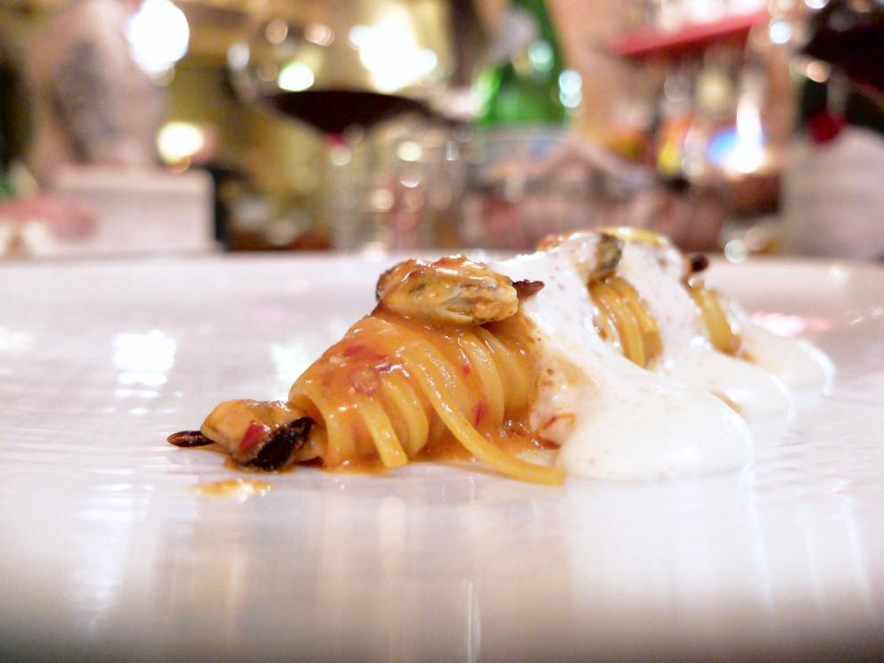 Photogallery






Our dinner at Cum Quibus in San Gimignano, portrayed by Tanio Liotta. We start with Fake green olive, garlic, oil and chilli pepper, olive crumble 









Mezzovo®: egg yolk, soffice di pecorino di Pienza, truffle, a classic by Sparacino. It’s even a trademark...









Pearl of liver with squid ink. Very good and persistent









Pizza liquida: mousse of bread, tomato, anchovies, oregano









Squid, panzanella, Parmigiano, basil, balsamic vinegar. The squid is seared, filled with panzanella, plus tomato jus, drops of balsamic vinegar, a wafer of Parmigiano and both fresh and fried basil









Bufala di capra e tartufo: fake mozzarella made with a mousse of goat cheese









Liver, mackerel, vinsanto, capers, lard









Foie gras Bavarian mousse, gel of miso, liquorice, chilli pepper, shallot, sea weeds. Great balance, a very elegant and aromatic dish









Buttons of lamb sweetbreads, garam masala, sour cream, fennel









Cannelloni with rabbit and puttanesca scauce






