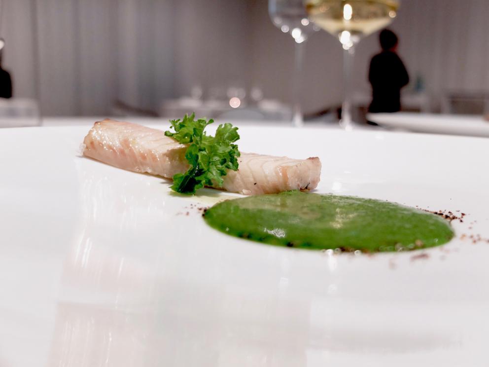 Photogallery






Water, oil, lemon and liquorice: purity. «I use it to clean the palate before the tasting. Water is energy, liquorice is synergic strength, lemon is my emblem, oil [chilled at -40°C] is my homeland»









Italy is also about bread. Taglienti makes it himself, with a 200-year-old mother yeast. On the small plate, at least two delicious types: whole wheat bread, to the right, and schiacciata with herbs and courgette flowers and dehydrated citrus fruits









A dish that, within this new tasting menu, represents something different, that is to say a hint to what the chef has done so far: Bianco e nero di seppia was born in 2009: «The input was a dish of spaghetti with squid ink I had on the beach in Sicily». Under the squid, pressed as if it were pasta, eight types of citrus fruits and panna cotta with sea urchins. Extracts, fonds and jus are increasingly essential in the cuisine of Taglienti. Through them, he channels the essence of flavour: «We always have 12 sauces in the kitchen: fonds of every possible meat, 6 juices from every citrus fruit, plus extracts». The photo shows a previous dinner we had. The author is Tanio Liotta









«I asked myself, why not serve saltimbocca alla romana?». Here it is: raw Piedmontese meat, culatello, butter emulsified with a little flour, thus adding a classic saltimbocca element, then an extract of sage and white wine – the sage is previously micro-fermented close to the stove. «In France cuisine is only about fine dining. In Italy, cuisine comprises everything». Taglienti uses the word vision for this dish









Fat goose liver from Mortara wrapped in steamed cabbage, warm oyster cream and casseoula sauce: the expression of a territory. «This is my idea of casseoula, which we cook in a classic way, and then extract so as to make a sauce». The cabbage recalls caponet or lattuga ripiena alla ligure (served with tocco, a thick meat broth which we’ll mention later too), but has fat liver too. A fantastic dish









Traditional Lasagne Bolognese: (new) avant-garde. A very thin dough, with the ragù simmering for six hours









Frittura di pesce morone al salmoriglio: heritage. «Here’s salmoriglio [not in the photo] an ancient Sicilian and Calabrian seasoning that is more and more forgotten and was one used for chargrilled fish» (olive oil, garlic, oregano, lemon juice, basil, fresh hot green chilli pepper). The batter is made with beer and encloses the fried fish as well as a sauce that is halfway between Provencal anchoiade, with anchovies, and Ligurian tapenade, with olives. Then, also fried in batter, a leaf of basil from the south, «because it’s large, while the basil from Prà in Liguria has small leaves» and then bergamot, Moroccan preserved lemon, olives form Arma di Taggia. Very good









Quintessenza di un tocco genovese: culinary memories. We’ve already mentioned tocco: it’s a sauce based on the very slow cooking of vegetables, tomatoes, mushrooms, bone marrow and then the meat you add so it releases its juices and flavours, and is served separately as a main course. Tocco is a concentrate of aromas that stays in the background. It’s a seasoning, usually, but Taglienti serves it by itself. An elegant blast of flavour









Artichoke cake: evolution. Taglienti adds an idea of tarte tatin to a classic. And a touch of Cynar. A dish halfway between savoury and sweet









Cappuccino of mushrooms with liver pudding: Italian classicism. This sweet is a small masterpiece: liver royale, black cherries, mushroom cappuccino, bay leaves, black pepper and vermouth. Extremely good, complex, and elegant









He also serves the previous dish in a less sweet version, as an entrée. We tasted it during a dinner a few months ago, when we took the following photos, which show the differences with the new road Taglienti has now taken. In this case, Mushrooms and veal liver royale. Tanio Liotta is the author of all the photos









We started with Water, oil, lemon and liquorice, in a slightly different version









Almond and tarragon, lovely









Lightly seared scampi from Liguria, chopped tomatoes in Vierge sauce and Genovese biscuit with basil from Prà









Oyster and hazelnut, a masterpiece






