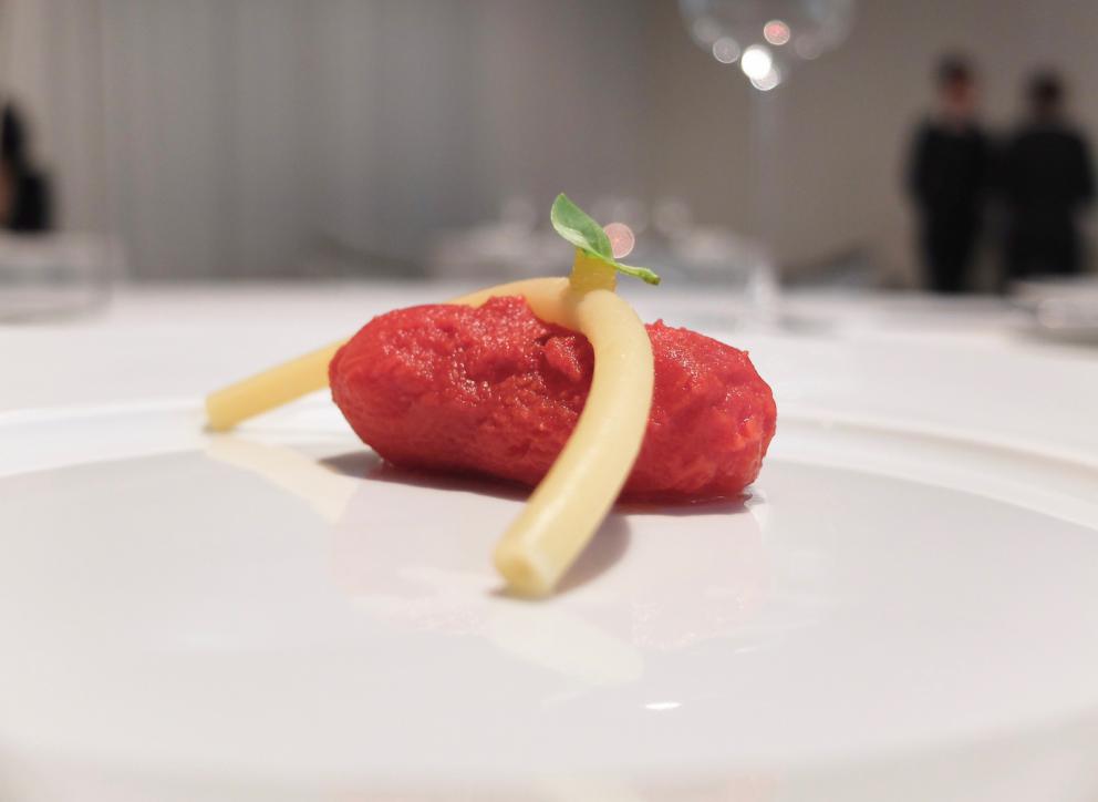 Photogallery






Water, oil, lemon and liquorice: purity. «I use it to clean the palate before the tasting. Water is energy, liquorice is synergic strength, lemon is my emblem, oil [chilled at -40°C] is my homeland»









Italy is also about bread. Taglienti makes it himself, with a 200-year-old mother yeast. On the small plate, at least two delicious types: whole wheat bread, to the right, and schiacciata with herbs and courgette flowers and dehydrated citrus fruits









A dish that, within this new tasting menu, represents something different, that is to say a hint to what the chef has done so far: Bianco e nero di seppia was born in 2009: «The input was a dish of spaghetti with squid ink I had on the beach in Sicily». Under the squid, pressed as if it were pasta, eight types of citrus fruits and panna cotta with sea urchins. Extracts, fonds and jus are increasingly essential in the cuisine of Taglienti. Through them, he channels the essence of flavour: «We always have 12 sauces in the kitchen: fonds of every possible meat, 6 juices from every citrus fruit, plus extracts». The photo shows a previous dinner we had. The author is Tanio Liotta









«I asked myself, why not serve saltimbocca alla romana?». Here it is: raw Piedmontese meat, culatello, butter emulsified with a little flour, thus adding a classic saltimbocca element, then an extract of sage and white wine – the sage is previously micro-fermented close to the stove. «In France cuisine is only about fine dining. In Italy, cuisine comprises everything». Taglienti uses the word vision for this dish









Fat goose liver from Mortara wrapped in steamed cabbage, warm oyster cream and casseoula sauce: the expression of a territory. «This is my idea of casseoula, which we cook in a classic way, and then extract so as to make a sauce». The cabbage recalls caponet or lattuga ripiena alla ligure (served with tocco, a thick meat broth which we’ll mention later too), but has fat liver too. A fantastic dish









Traditional Lasagne Bolognese: (new) avant-garde. A very thin dough, with the ragù simmering for six hours









Frittura di pesce morone al salmoriglio: heritage. «Here’s salmoriglio [not in the photo] an ancient Sicilian and Calabrian seasoning that is more and more forgotten and was one used for chargrilled fish» (olive oil, garlic, oregano, lemon juice, basil, fresh hot green chilli pepper). The batter is made with beer and encloses the fried fish as well as a sauce that is halfway between Provencal anchoiade, with anchovies, and Ligurian tapenade, with olives. Then, also fried in batter, a leaf of basil from the south, «because it’s large, while the basil from Prà in Liguria has small leaves» and then bergamot, Moroccan preserved lemon, olives form Arma di Taggia. Very good









Quintessenza di un tocco genovese: culinary memories. We’ve already mentioned tocco: it’s a sauce based on the very slow cooking of vegetables, tomatoes, mushrooms, bone marrow and then the meat you add so it releases its juices and flavours, and is served separately as a main course. Tocco is a concentrate of aromas that stays in the background. It’s a seasoning, usually, but Taglienti serves it by itself. An elegant blast of flavour









Artichoke cake: evolution. Taglienti adds an idea of tarte tatin to a classic. And a touch of Cynar. A dish halfway between savoury and sweet









Cappuccino of mushrooms with liver pudding: Italian classicism. This sweet is a small masterpiece: liver royale, black cherries, mushroom cappuccino, bay leaves, black pepper and vermouth. Extremely good, complex, and elegant









He also serves the previous dish in a less sweet version, as an entrée. We tasted it during a dinner a few months ago, when we took the following photos, which show the differences with the new road Taglienti has now taken. In this case, Mushrooms and veal liver royale. Tanio Liotta is the author of all the photos









We started with Water, oil, lemon and liquorice, in a slightly different version









Almond and tarragon, lovely









Lightly seared scampi from Liguria, chopped tomatoes in Vierge sauce and Genovese biscuit with basil from Prà









Oyster and hazelnut, a masterpiece









Eel and turnip tops 









Lobster and white snails potage 






