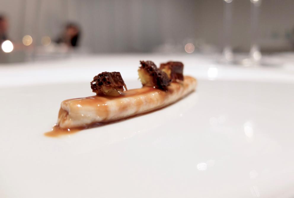 Photogallery






Water, oil, lemon and liquorice: purity. «I use it to clean the palate before the tasting. Water is energy, liquorice is synergic strength, lemon is my emblem, oil [chilled at -40°C] is my homeland»









Italy is also about bread. Taglienti makes it himself, with a 200-year-old mother yeast. On the small plate, at least two delicious types: whole wheat bread, to the right, and schiacciata with herbs and courgette flowers and dehydrated citrus fruits









A dish that, within this new tasting menu, represents something different, that is to say a hint to what the chef has done so far: Bianco e nero di seppia was born in 2009: «The input was a dish of spaghetti with squid ink I had on the beach in Sicily». Under the squid, pressed as if it were pasta, eight types of citrus fruits and panna cotta with sea urchins. Extracts, fonds and jus are increasingly essential in the cuisine of Taglienti. Through them, he channels the essence of flavour: «We always have 12 sauces in the kitchen: fonds of every possible meat, 6 juices from every citrus fruit, plus extracts». The photo shows a previous dinner we had. The author is Tanio Liotta









«I asked myself, why not serve saltimbocca alla romana?». Here it is: raw Piedmontese meat, culatello, butter emulsified with a little flour, thus adding a classic saltimbocca element, then an extract of sage and white wine – the sage is previously micro-fermented close to the stove. «In France cuisine is only about fine dining. In Italy, cuisine comprises everything». Taglienti uses the word vision for this dish









Fat goose liver from Mortara wrapped in steamed cabbage, warm oyster cream and casseoula sauce: the expression of a territory. «This is my idea of casseoula, which we cook in a classic way, and then extract so as to make a sauce». The cabbage recalls caponet or lattuga ripiena alla ligure (served with tocco, a thick meat broth which we’ll mention later too), but has fat liver too. A fantastic dish









Traditional Lasagne Bolognese: (new) avant-garde. A very thin dough, with the ragù simmering for six hours









Frittura di pesce morone al salmoriglio: heritage. «Here’s salmoriglio [not in the photo] an ancient Sicilian and Calabrian seasoning that is more and more forgotten and was one used for chargrilled fish» (olive oil, garlic, oregano, lemon juice, basil, fresh hot green chilli pepper). The batter is made with beer and encloses the fried fish as well as a sauce that is halfway between Provencal anchoiade, with anchovies, and Ligurian tapenade, with olives. Then, also fried in batter, a leaf of basil from the south, «because it’s large, while the basil from Prà in Liguria has small leaves» and then bergamot, Moroccan preserved lemon, olives form Arma di Taggia. Very good









Quintessenza di un tocco genovese: culinary memories. We’ve already mentioned tocco: it’s a sauce based on the very slow cooking of vegetables, tomatoes, mushrooms, bone marrow and then the meat you add so it releases its juices and flavours, and is served separately as a main course. Tocco is a concentrate of aromas that stays in the background. It’s a seasoning, usually, but Taglienti serves it by itself. An elegant blast of flavour









Artichoke cake: evolution. Taglienti adds an idea of tarte tatin to a classic. And a touch of Cynar. A dish halfway between savoury and sweet









Cappuccino of mushrooms with liver pudding: Italian classicism. This sweet is a small masterpiece: liver royale, black cherries, mushroom cappuccino, bay leaves, black pepper and vermouth. Extremely good, complex, and elegant









He also serves the previous dish in a less sweet version, as an entrée. We tasted it during a dinner a few months ago, when we took the following photos, which show the differences with the new road Taglienti has now taken. In this case, Mushrooms and veal liver royale. Tanio Liotta is the author of all the photos









We started with Water, oil, lemon and liquorice, in a slightly different version









Almond and tarragon, lovely









Lightly seared scampi from Liguria, chopped tomatoes in Vierge sauce and Genovese biscuit with basil from Prà









Oyster and hazelnut, a masterpiece









Eel and turnip tops 









Lobster and white snails potage 









Pummarola e mezzanello









Risotto with freshly pressed turmeric juice, wild black pepper and powdered bay leaves 






