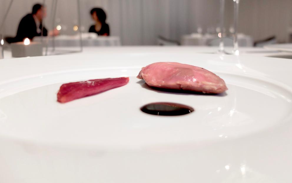 Photogallery






Water, oil, lemon and liquorice: purity. «I use it to clean the palate before the tasting. Water is energy, liquorice is synergic strength, lemon is my emblem, oil [chilled at -40°C] is my homeland»









Italy is also about bread. Taglienti makes it himself, with a 200-year-old mother yeast. On the small plate, at least two delicious types: whole wheat bread, to the right, and schiacciata with herbs and courgette flowers and dehydrated citrus fruits









A dish that, within this new tasting menu, represents something different, that is to say a hint to what the chef has done so far: Bianco e nero di seppia was born in 2009: «The input was a dish of spaghetti with squid ink I had on the beach in Sicily». Under the squid, pressed as if it were pasta, eight types of citrus fruits and panna cotta with sea urchins. Extracts, fonds and jus are increasingly essential in the cuisine of Taglienti. Through them, he channels the essence of flavour: «We always have 12 sauces in the kitchen: fonds of every possible meat, 6 juices from every citrus fruit, plus extracts». The photo shows a previous dinner we had. The author is Tanio Liotta









«I asked myself, why not serve saltimbocca alla romana?». Here it is: raw Piedmontese meat, culatello, butter emulsified with a little flour, thus adding a classic saltimbocca element, then an extract of sage and white wine – the sage is previously micro-fermented close to the stove. «In France cuisine is only about fine dining. In Italy, cuisine comprises everything». Taglienti uses the word vision for this dish









Fat goose liver from Mortara wrapped in steamed cabbage, warm oyster cream and casseoula sauce: the expression of a territory. «This is my idea of casseoula, which we cook in a classic way, and then extract so as to make a sauce». The cabbage recalls caponet or lattuga ripiena alla ligure (served with tocco, a thick meat broth which we’ll mention later too), but has fat liver too. A fantastic dish









Traditional Lasagne Bolognese: (new) avant-garde. A very thin dough, with the ragù simmering for six hours









Frittura di pesce morone al salmoriglio: heritage. «Here’s salmoriglio [not in the photo] an ancient Sicilian and Calabrian seasoning that is more and more forgotten and was one used for chargrilled fish» (olive oil, garlic, oregano, lemon juice, basil, fresh hot green chilli pepper). The batter is made with beer and encloses the fried fish as well as a sauce that is halfway between Provencal anchoiade, with anchovies, and Ligurian tapenade, with olives. Then, also fried in batter, a leaf of basil from the south, «because it’s large, while the basil from Prà in Liguria has small leaves» and then bergamot, Moroccan preserved lemon, olives form Arma di Taggia. Very good









Quintessenza di un tocco genovese: culinary memories. We’ve already mentioned tocco: it’s a sauce based on the very slow cooking of vegetables, tomatoes, mushrooms, bone marrow and then the meat you add so it releases its juices and flavours, and is served separately as a main course. Tocco is a concentrate of aromas that stays in the background. It’s a seasoning, usually, but Taglienti serves it by itself. An elegant blast of flavour









Artichoke cake: evolution. Taglienti adds an idea of tarte tatin to a classic. And a touch of Cynar. A dish halfway between savoury and sweet









Cappuccino of mushrooms with liver pudding: Italian classicism. This sweet is a small masterpiece: liver royale, black cherries, mushroom cappuccino, bay leaves, black pepper and vermouth. Extremely good, complex, and elegant









He also serves the previous dish in a less sweet version, as an entrée. We tasted it during a dinner a few months ago, when we took the following photos, which show the differences with the new road Taglienti has now taken. In this case, Mushrooms and veal liver royale. Tanio Liotta is the author of all the photos









We started with Water, oil, lemon and liquorice, in a slightly different version









Almond and tarragon, lovely









Lightly seared scampi from Liguria, chopped tomatoes in Vierge sauce and Genovese biscuit with basil from Prà









Oyster and hazelnut, a masterpiece









Eel and turnip tops 









Lobster and white snails potage 









Pummarola e mezzanello









Risotto with freshly pressed turmeric juice, wild black pepper and powdered bay leaves 









Veal and cinnamon sticks 






