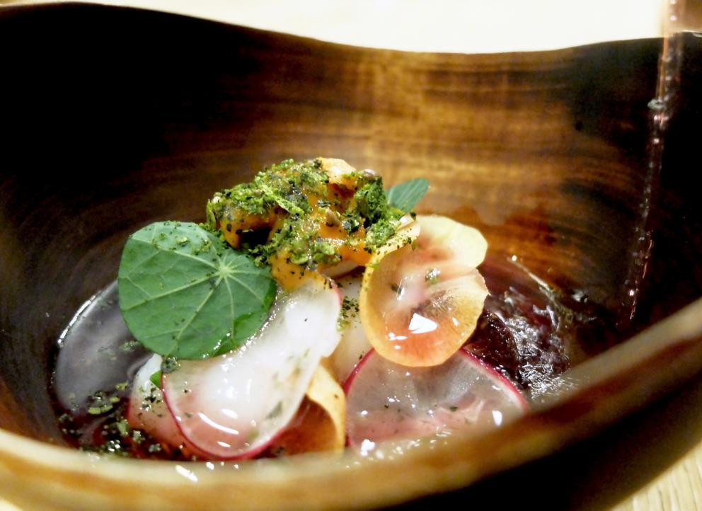 PhotogalleryThe tasting at Tokuyoshi&rsquo;s begins with Lacrime di verdura, mottainai broth, which is the Japanese to say &ldquo;what a waste&rdquo;, more or less. It&rsquo;s made with vegetable scraps, infused for 48 hours. It&rsquo;s delicious. The first tasting &ndash; the photos are by Tanio Liotta&nbsp;&ndash; is the sweet and savoury Crostatina di melanzane alla parmigiana
Pianta & radici, scampi in tempura with vegetal carbon
Sicilian cannoli filled with creamed salted cod 
Pizza Anna, a light version of pizza capricciosa, to share: the base is made with puffed rice, then tomato sauce, wafers of Parmigiano, cooked ham, mortadella, capers, anchovies and fried artichokes. Paired with a broth of capers
