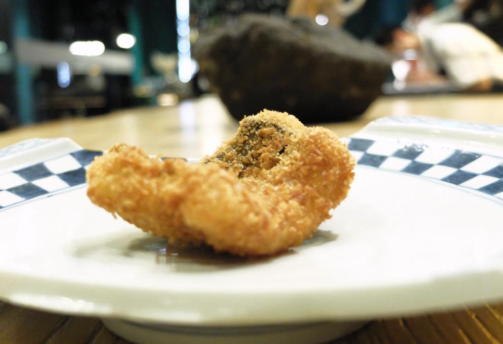 PhotogalleryThe tasting at Tokuyoshi&rsquo;s begins with Lacrime di verdura, mottainai broth, which is the Japanese to say &ldquo;what a waste&rdquo;, more or less. It&rsquo;s made with vegetable scraps, infused for 48 hours. It&rsquo;s delicious. The first tasting &ndash; the photos are by Tanio Liotta&nbsp;&ndash; is the sweet and savoury Crostatina di melanzane alla parmigiana
Pianta & radici, scampi in tempura with vegetal carbon
Sicilian cannoli filled with creamed salted cod 
Pizza Anna, a light version of pizza capricciosa, to share: the base is made with puffed rice, then tomato sauce, wafers of Parmigiano, cooked ham, mortadella, capers, anchovies and fried artichokes. Paired with a broth of capers
Tanti cilindri: scallops, roots, Breton sea urchins, plankton, black cabbage, carrot, cherries, peach, radish, nasturtium, fermented carrot juice... A fantastic, very elegant dish
