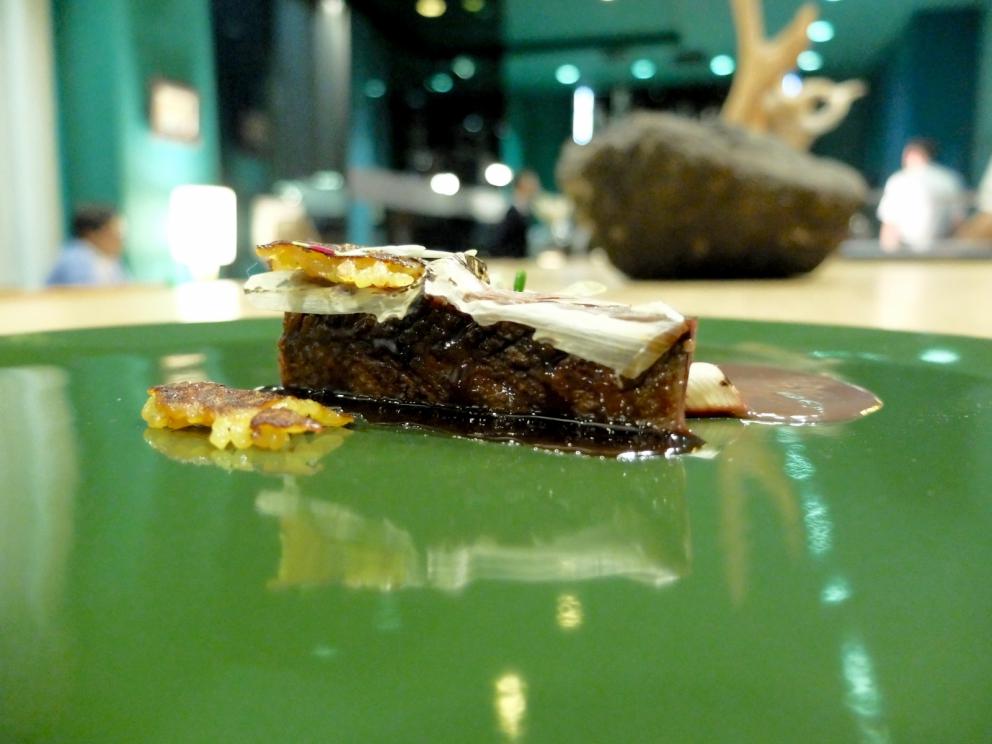 PhotogalleryThe tasting at Tokuyoshi&rsquo;s begins with Lacrime di verdura, mottainai broth, which is the Japanese to say &ldquo;what a waste&rdquo;, more or less. It&rsquo;s made with vegetable scraps, infused for 48 hours. It&rsquo;s delicious. The first tasting &ndash; the photos are by Tanio Liotta&nbsp;&ndash; is the sweet and savoury Crostatina di melanzane alla parmigiana
Pianta & radici, scampi in tempura with vegetal carbon
Sicilian cannoli filled with creamed salted cod 
Pizza Anna, a light version of pizza capricciosa, to share: the base is made with puffed rice, then tomato sauce, wafers of Parmigiano, cooked ham, mortadella, capers, anchovies and fried artichokes. Paired with a broth of capers
Tanti cilindri: scallops, roots, Breton sea urchins, plankton, black cabbage, carrot, cherries, peach, radish, nasturtium, fermented carrot juice... A fantastic, very elegant dish
Da leccarsi le dita: delicious eel rolled in panko, Japanese Amakusa salt (very mineral), pepper. You dip it in furikake sauce, made with fish and capon stock, with pepper from Makuaw, Taiwan, very citrusy
Ginger beer and lemon grass to cleanse the palate
Tagliatelle, lardo di wagyu di Kyoto, foglia di pomodoro: homemade tagliatelle made with lard from Japanese beef prepared by Tokuyoshi&nbsp;according to Italian tradition and matured 2 months, then bergamot and Parmigiano. Paired with Via Emilia broth, with capon, crust of Parmigiano, prosciutto and mortadella
Lingua &&nbsp;coda: veal tongue and monkfish, seasoned sauces made with their respective jus, the latter adding some tomato water, plus turnip tops and broth of capers
Deer fillet from Zivieri, pur&eacute;e of purple potatoes, leek, black truffle from the Apennine. The meat is glazed in mottainai broth and teriaki. Paired with a broth of red fruits and beetroot. A great dish
