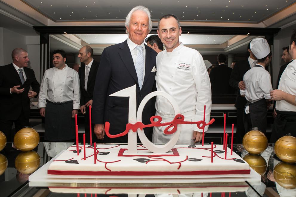 Photogallery






Together with the celebration, the report of a recent dinner at Imago inside hotel Hassler, with chef Francesco Apreda, much appreciated at Identità both professionally and as a person. As we said on the Guida Identità Golose 2017, "if you think about it, it’s a nice paradox: in the Eternal City, from the 6th floor of hotel Hassler, there’s a talented chef from Campania who makes you travel around the world for a few hours. There’s enough to make you forget the stereotype according to which Rome is so full of history it’s just concentrated on itself, and thus provincial". (Carlo Passera)









We start with Celeriac, peppers and ginger; Daikon with yuzu and black truffle; Radish with lime and gin: all in osmosis. There’s technique at the service of the creative mind, resulting in a debut that prepares the palate whetting the appetite. Followed by Egg in tempura, lime and fig mustard: delicious without trying hard to please









Foie gras and scones, Sweet Rain blend (2015): this, like most of the dishes by Apreda, is characterised by the blend of spices that originate from the chef’s long experience around the world (see also: I Sapori di Viaggio di Apreda). It was part of the "menu 10 anni"









Apreda with his blends. As we mentioned, the chef "interacts with the client, mixes territories and stories, draws from his experience in every continent and sums this up in spicy inspiration: he may add Napoli, Mumbai, and so on (he studied and defined a total of six aromas, each with a precise geographic origin: so it’s enough to add a pinch of London or New York. Your taste buds will be thankful "). The next dish, among the new ones in the menu, is truly fantastic: Seafood vegetable minestrone. One of the best, in a tasting menu that always has the highest quality. In this case potatoes, onion, celery, baby spinach, leek and parmigiano wafer meet a seafood broth made with kombu seaweed









Mozzarella di bufala INConsistenza, scapece di appiccatelli vesuviani, another voluptuous dish in the menu. Different textures of mozzarella (as a film, dehydrated, in a mousse, a sauce, in pieces, in gel...) with a pinch of Napoli, yet in the sense of a mix of herbs recalling the city









Scallop shabu in a carpaccio, yuzu and black truffle, turning upside down the litany of a mollusc often overused in fine dining, making its taste once again interesting. The photo, however, is of the Breaded scallops, shitake and black truffle, from 2007, in the anniversary menu: the same applies. The scallops filled with buffalo milk mozzarella, truffle and celery leaves had a different breading, instead of the classic Milanese style (breadcrumbs and flour) there’s now panko (Japanese breadcrumbs) and dry Indian rice flakes, while the sauce is made richer with shitake mushrooms: the dish, thus assembled, is served with a broth on the side, so as to enhance its textures. This is also Roberto E. Wirth’s favourite dish









Octopus and seaweeds, roots and Uma-Mia blend (2016): as in the case of the scallops, Apreda is never banal









The starters finish with a Tartare of prawns and veal tongue, puntarelle and ponzu









This is a great classic of the chef, deservingly celebrated: Cappellotti Double Umami (Blend Spicy Bomba-y). A contrast of temperatures: the filling of the pasta, made with parmigiano and katsuobushi, is hot, while the broth, made with tuna and double malt beer is cold. Trenette with shiso pesto, squilla mantis and potatoes and Risotto with red onion and foie gras, spicy powdered coffee, two new dishes









In the anniversary menu, there was a different risotto: Risotto cacio pepi e sesami, from 2012 (he added pecorino water, made by blending pecorino in hot water, then placing the mixture in the fridge: the fat solidifies on top, the proteins fall below while in the centre there’s the water in which they cook the risotto)...









... Capellini garlic oil chilli pepper and smoked eel, from 2008: cocoa was used in the past, while he now uses only cocoa beans adding a bitter taste. The chef smokes the eel himself









Black cod and purple vegetables, succulence from 2009: fermented cabbage, sauce of purple potatoes, black aubergine and violets. In the contemporary menu, a remarkable Roasted monkfish with olives and ginger, pumpkin and chanterelle mushrooms 









Chicken in two cultures, pepper and teriyaki is one of the must-taste when dining at Apreda’s. His idea of presenting chicken, often snubbed by fine dining, in a completely different way, is brilliant









The chef says: "The initial idea was to include a chicken to be served as a whole. Something rare in restaurants. But the wish to eat a good roast chicken is closely connected to traditional home-made food and I wanted to make this wish come true at Imàgo"









And then: "After a month of experiments we combined two cultures in just one chicken: one cooking and two cultures, that is to say chicken with pepper, typical of Roman tradition, with a Japanese inspired teriyaki glazing. There was a real study to elaborate what the chicken at Imàgo had to be like. The final dish is the result of teamwork: everyone contributed in creating the best method to have the perfect chicken”. See: Chicken in two cultures









A relatively recent alternative to the chicken is Duck in Tandoori style (2014). It’s enriched with Chinese cabbage. Its texture and colour is revived by dipping it into water and putting it in vacuum pack









Samosa with sfogliatella napoletana (2011): a glocal dish. Here they worked with the pastry: after researching the recipe for Samosa at length, he finally found the Indian method and starte to make it itself. With its crispiness it’s a good match for litchi, coconut and yogurt









The sweets begin: Winter sphere, ricotta and mandarin with darjeeling tea and, in the photo, Babà in sospensione al cacao e rhum, orzata e ghiacciato alla banana









The dessert celebrating the anniversary was Dolce mozzarella di bufala (2013): in which he uses beetroot instead of the fruits of the forest while the fake mozzarella is made by mixing buffalo milk, buffalo yogurt and white chocolate









I was literally struck by this dessert, already in its previous version (with lots of red fruit grattacheca, toffee with balsamic vinegar and crumble) which Apreda presented at Identità Expo. Unforgettable, it’s enough to quality a great chef and his brilliant pastry chef, Dario Nuti. Click here for the recipe, photo by  Brambilla-Serrani






