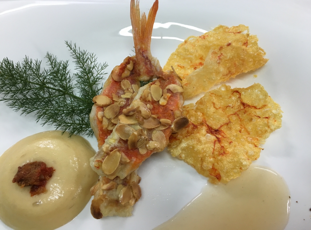 Photogallery






Gianni Dezio, Tosto, Atri (Teramo)

Tortelli with artichokes, fondue of pecorino from Atri, mint and liquorice. Liquorice and mint unite so as to enhance one of the most important vegetables in Italian cuisine









Valerio Centofanti, L'Angolo d'Abruzzo, Carsoli (L'Aquila)

Pappardelle with gelded lamb with pecorino from Alta Valle del Turano. The lamb is gelded before it is two months’ old and raised for 18 months. A dish full of emotions and sensations that has disappeared from Italian kitchens (in the picture, the gelded lamb)









Niko Romito, Reale Casadonna, Castel di Sangro (L'Aquila)

Because it’s the proof that constant research in the kitchen (in this case applied to cutting and macerating cabbage) can pull down the "wall" of vegetal representation and give new and powerful solutions in terms of structure and taste. Creating surprise and deep emotion. For me, it represents a new phase









Mattia Spadone, La Bandiera, Civitella Casanova (Pescara)

Vegetables cooked in salt. I worked on cooking in salt only using vegetables (from our kitchen garden). It may seem banal but I’ve been working on this for over 3 months: these are roots and leaves presented in different textures, crispy, mashed and thinly diced









Patrizia Corradetti, Zenobi, Colonnella (Teramo)

Meat and spinach ravioli with Neapolitan genovese sauce. I needed to include in the mid-August menu a first course with filled pasta that would still be traditional









Nadia Moscardi, Elodia nel Parco, L'Aquila

Textures of pasta and vegetable garden. It is inspired by Le Virtù, an ancient soup from Abruzzo that was made by the bride for the future mother-in-law to prove her virtues in the kitchen










William Zonfa, Magione Papale, L'Aquila

Castratissimo. Gelded meat is very popular in Abruzzo. The sauce you see is a dehydrated “veil of gelded meat sauce”, wrapping the soft meat. Upon contact with the heat and humidity of the meat, it is rehydrated and gives life to the memory of meat chops coming out from the sauce itself









Cinzia Mancini, Bottega Culinaria Biologica, San Vito Chietino (Chieti)

Pescatrice noir. My territory and the elements defining it: sun, rocks, sea, wind and fire









Stefania Di Pasquo, Locanda Mammì, Agnone (Isernia)

Raspberry mousse with caramelised white chocolate and hazelnuts. It’s a non-sweet sweet, a dessert that represents a change from the classic desserts I have in the menu. It represents my current desire for change









Felice Sgarra, Umami, Andria

Cream of cannellini beans and scampi with lemon sourness. A fresh course but also one that is suitable for every occasion
 









Antonio Scalera, La Bul, Bari

Home-smoked mackerel, toasted walnuts, jam and gelatine of friggitelli peppers. Blue tailed fish: poor, from the tradition and history of Apulia. Cinderella becomes the queen on our table









Giovanni Lorusso, Memory resort, Bisceglie (Barletta, Andria e Trani)

Sea bass, smoked Jerusalem artichoke, green affilla and sesame praliné. The fish, the aroma of almonds, the sauce of smoked Jerusalem artichoke, the aroma of the baby peas that have just sprouted and the sesame praliné adding sweetness and balsamic notes









Teresa Galeone Buongiorno, Già Sotto l'Arco, Carovigno (Brindisi)

Pink gnocchi with pesto heart, ricotta and puffed beetroot. A voluptuous mix of colours and flavours









Antonella Ricci and Vinod Sookar, Al Fornello da Ricci, Ceglie Messapica (Brindisi)

Drops of ricotta on a pesto of wild chards, crispy pancetta and pepper smoked with apple wood. The brackish note of the chards enhances the milky taste of the ricotta, strictly produced by Mrs Anna Argentiero. In this season there’s the best ricotta and wild chards. In the menu until April









Francesco Nacci, Botrus, Ceglie Messapica (Brindisi)

I wanted to be a chop. Smoked carpaccio with olive leaves where the "thinness" substitutes the "long cooking time" and the creams with classic flavours (tomato, pecorino, capers) give it the softness and succulence of a homemade "braciola al sugo" (chop with tomato sauce)
 









Filomena Silibello, Cibus, Ceglie Messapica (Brindisi)

Quail soup with simeto durum wheat, chicory and wild scattapietre. The hunting tradition of this territory and the richness of wild herbs induced our grandmothers to serve all that nature had to offer locally









Salvatore Amato, Borgo Valle Rita, Ginosa (Taranto)

Risotto with burnt garlic, oil, chilli pepper and sea urchins. Our agricultural tradition and all the elegance of the sea melt in a dish capable of recalling the best childhood memories









Alfredo De Luca, Malcandrino, Lecce

Risotto, sorbet of red onion from Tropea, chicken liver, radishes and wild fennel. The well-established match of onions and liver becomes an explosion thanks to rice









Angelo Sabatelli, Angelo Sabatelli, Monopoli (Bari)

Squid, allievo (baby squid), almond and lemon. A dish that encloses all of Apulia in 3 ingredients: squid (in two versions: the adult for the veil and the baby served raw), candied lemon from Gargano and cream of almonds from Toritto (photo by Lello D'Anna)









Pietro Zito, Antichi Sapori, Montegrosso (Andria) 

Black chard lasagne stuffed with pancotto with turnip tops and potatoes. For us, real farmers, who grew up in the old countryside, vegetarian and vegan cuisine were everyday life. A few days ago I introduced this deceivable dish in the menu: there’s no meat, no egg, no cheese. Still, it is good and looks good






