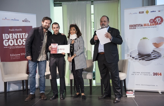 Galleria fotografica






La settima edizione della Guida Identità Golose ai ristorante d'autore in Italia e nel mondo









La sala gremita del Magna Pars Suite MIlano in via Forcella 6 a Milano








I Migliori chef per la Guida di Identità Golose 2014 sono Alessandro Negrini e Fabio Pisani de Il Luogo di Aimo e Nadia a Milano. Con loro sul palco, il sommelier Nicola Dell'Agnolo e Stefania Moroni. A premiarli Carlo Bianchi, area manager di Cavit. A destra, Paolo Marchi, curatore della Guida di Identità 2014.








Alessandro Negrini e Fabio Pisani "depositano" la loro impronta d'autore








La Migliore chef donna è Sara Preceruti de La Locanda del Notaio di Pellio Intelvi (Como), menzione speciale Sognatori del Gusto. Premia Marco Barbieri, International Relations Team di S.Pellegrino.








Sara Preceruti








Paolo Marchi con Oscar Farinetti, autore della prefazione della guida








Il Miglior chef straniero 2014 è Kobe Desramaults del ristorante In de Wulf a Heuvelland nelle Fiandre, in Belgio. Premia Serena Stefanoni de il Consorzio Grana Padano. Con loro Gabriele Zanatta (a sinistra), caporedattore della guida, e Paolo Marchi








Kobe Desramaults








Il Miglior sous chef è Alessandro Procopio del ristorante D’O di Cornaredo (Milano), chef Davide Oldani (in foto, a sinistra). È premiato da Sara Peirone, responsabile Top Gastronomy di Lavazza.








Paolo Marchi con Carlo Cracco, autore della prefazione dolce








Paolo Marchi con Massimo Bottura, autore del racconto di Modena





