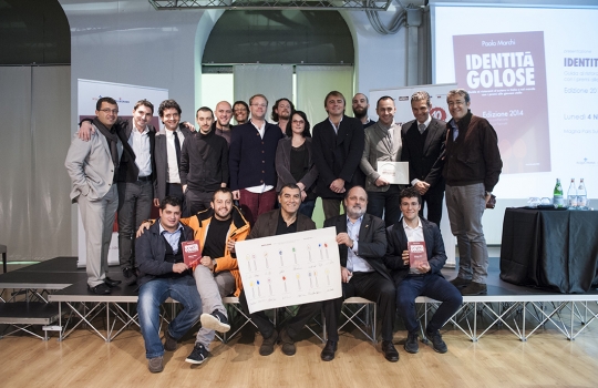 Galleria fotografica






La settima edizione della Guida Identità Golose ai ristorante d'autore in Italia e nel mondo









La sala gremita del Magna Pars Suite MIlano in via Forcella 6 a Milano








I Migliori chef per la Guida di Identità Golose 2014 sono Alessandro Negrini e Fabio Pisani de Il Luogo di Aimo e Nadia a Milano. Con loro sul palco, il sommelier Nicola Dell'Agnolo e Stefania Moroni. A premiarli Carlo Bianchi, area manager di Cavit. A destra, Paolo Marchi, curatore della Guida di Identità 2014.








Alessandro Negrini e Fabio Pisani "depositano" la loro impronta d'autore








La Migliore chef donna è Sara Preceruti de La Locanda del Notaio di Pellio Intelvi (Como), menzione speciale Sognatori del Gusto. Premia Marco Barbieri, International Relations Team di S.Pellegrino.








Sara Preceruti








Paolo Marchi con Oscar Farinetti, autore della prefazione della guida








Il Miglior chef straniero 2014 è Kobe Desramaults del ristorante In de Wulf a Heuvelland nelle Fiandre, in Belgio. Premia Serena Stefanoni de il Consorzio Grana Padano. Con loro Gabriele Zanatta (a sinistra), caporedattore della guida, e Paolo Marchi








Kobe Desramaults








Il Miglior sous chef è Alessandro Procopio del ristorante D’O di Cornaredo (Milano), chef Davide Oldani (in foto, a sinistra). È premiato da Sara Peirone, responsabile Top Gastronomy di Lavazza.








Paolo Marchi con Carlo Cracco, autore della prefazione dolce








Paolo Marchi con Massimo Bottura, autore del racconto di Modena








Il miglior chef pasticciere è Luca Sacchi del ristorante Cracco a Milano. Premia Cristina Trolli di Zafferano 3 Cuochi. Con loro, lo chef Carlo Cracco e Paolo Marchi








Luca Sacchi, Miglior Chef Pasticciere 2014








Il Premio Birra in cucina è di Daniele Usai del ristorante Il Tino di Ostia a Roma. A premiarlo per Birra Moretti, Alfredo Pratolongo, direttore Comunicazione e Affari istituzionali di Heineken Italia








Daniele Usai con il premio Caraiba e la guida








Nel corso della presentazione








La Miglior carta dei vini e distillati: Imago dell’Hotel Hassler di Roma. A ritirare il premio, il sommelier Marco Amato e lo chef Francesco Apreda. Premia Marco Ravasi, brand director Italy di Ruinart








Le firme di Marco Amato e Francesco Apreda








Il Miglior sommelier è Valerio Capriotti del ristorante Duomo di Ragusa Ibla, chef Ciccio Sultano (sul palco, a sinistra). Premia Carlo Mogolino, brand manager di Torre Rosazza








Valerio Capriotti








Il Miglior maître è Donato Marzolla, del ristorante Rossellinis del Palazzo Avino a Ravello (Salerno). Premia Tenuta Sant’Anna: in foto, Francesco Marchese, responsabile marketing e comunicazione de Le Tenute di Genagricola








Donato Marzolla








Il premio fornito, come ogni anno, da Caraiba: le porcellane Figgjio Norway
 








Sorpresa dell’anno: Beniamino Nespor ed Eugenio Roncoroni de Al Mercato di Milano. Premia Anna Maschio di Bonaventura Maschio








Eugenio Roncoroni (a sinistra) e Beniamino Nespor








La Giovane famiglia dell’anno: Mattia, Alessio con Bruna e Marcello Spadone del ristorante La Bandiera di Civitella Casanova, Pescara (a Milano c’erano Alessio e Marcello). A premiarli, Alfredo Zini, dell’Ente bilaterale nazionale del Turismo








Le firme di Alessio e Marcello Spadone








Miglior Giornalista, lo svedese Mattias Kroon (Sydsvenska Dagbladet e Mat&Vanner). Premia Anna Baccarani, ufficio marketing di Surgital. A sinistra Gabriele Zanatta e a destra Paolo Marchi








Mattias Kroon








Con Paolo Marchi, Giorgia Martone del Magna Pars Suites Milano e lo chef Fulvio Siccardi del ristorante Da Noi In








Gli autori di tre delle dodici città raccontate: da sinistra, Roberto Petza (Sardegna), Francesco Apreda (Roma) e Massimo Bottura (Modena)





