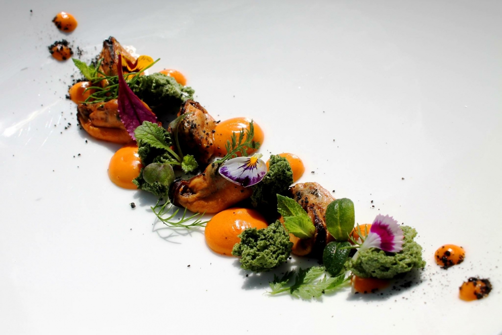 Photogallery






Iside De Cesare, La Parolina, Acquapendente (Viterbo)

Cod, garlic, oil and chilli pepper









Gianfranco Pascucci, Pascucci al Porticciolo, Fiumicino (Rome)

Eel tortelli in a broth of miso and caviar. Lake of Burano, WWF oasis: eel, myrtle and lentiscus. We’re collaborating with the WWF oases to give a "taste" to these places (photo by Andrea Di Lorenzo)









Claudio Petrolo, Claudio Petrolo, Gaeta (Latina)

Sea essence. Raw and cooked elements start an explosion with the flavour of the sea









Marco Bottega, Aminta resort, Genazzano (Rome)

Salmon, green apple and Orient spices. A meeting of sour, bitter, sweet and savoury









Rocco de Santis, Il Vistamare del Fogliano hotel, Latina

Red mullet in bread crust. A snack you can also eat with your hands, enclosing the scents of the South (I’m from Salerno): it’s like biting the sea together with onion, garlic, mint, lemon scents, raisins and pine nuts









Daniele Usai, Il Tino, Ostia (Rome)

Gnocchi with mandarin, with cod tripe and spinach. A historic dish from our menu has just returned in a current version









Gino Pesce, Acqua Pazza, Ponza (Latina)

Candele, cheese, pepper, white fish and courgettes. Created for a project we presented at Expo Milano with the goal of enhancing all the POD products of Lazio









Maurizio e Sandro Serva, La Trota, Rivodutri (Rieti)

Crayfish, roots, tubers, watercress with smoked trout and lake whitefish roe. A concentrate of flavours and lightness: roots, tubers and crayfish are steamed with aromatised water, with vegetable peels and Matcha tea. There’s no salt: the sapidity is giveb by the roe, the smokiness of the trout and the minerals in the vegetables and in the watercress, picked from our brook









Andrea Fusco, Giuda Ballerino, Rome

Venison sirloin with its jus and hibiscus, caramelised onions with blueberries and pistachio wafer. Serving a rich and lean red meat that is rarely served in this season









Cristina Bowerman, Glass Hostaria, Rome

Pasta and potatoes. Four different types of potatoes, with 4 different cooking methods, from mashed to crispy. Inspired by Bottura’s Compression of pasta and beans 









Anthony Genovese, Il Pagliaccio, Rome

Oyster, beetroot and coffee, snow of burrata. A journey across different scents, temperatures and textures









Francesco Apreda, Imàgo dell'hotel Hassler, Rome

Tandoori duck breast, cocoa earth and dried apricots. My personal take of a great classic from a continent I’m very fond of









Arcangelo Dandini, L'Arcangelo, Rome

My cipollata: zita with onion fondant with three spices. Taken from the Renaissance cipollata of Bartolomeo Scappi, the secret chef of 6 popes, who lived almost 30 years in Rome
 









Heinz Beck, La Pergola, Rome

S Campo. It’s the interpretation, with a modern take, of minestrone, made with lyophilisation. Each vegetable is cooked in the most suitable way so as to maintain its nutritional characteristics and then lyophilised. The result is 6, 7, 8 powders which are then put in the dish. The dish is served with scampi breaded with potatoes and soaked in front of the guest with a jus of this crustacean (photo by Janez Puksic)









Alba Esteve Ruiz, Marzapane, Rome

Chestnut cappeletti, raisins, smoked herring and seaweed infusion. Contrasts: the soft chestnut filling and a very persistent flavour, the smokiness and the fatness of the eel, the intense sweetness of the raisins, the sapidity of the seaweed infusion, the crispiness of the pasta...









Marco Baccanelli e Francesca Barreca, Mazzo, Rome

Roasted quails, baked tubers and roots, herb butter. The quails are served in their original shape, without deboning them. Our cuisine is moving towards a greater simplicity, and we can do so even by choosing classic yet not simple techniques









Roy Caceres, Metamorfosi, Roma

Mushrooms, flax brittle, black garlic and cream with Monviso blue cheese. In the seeming simplicity of an ingredient like mushrooms, contrasting textures give life to a dish in which their identity is surprisingly enhanced

 









Davide Del Duca, Osteria Fernanda, Rome

Snails, radish roots, Purgatorio beans, leaves and mustard seeds. A tribute to the material and primordial essence of the “earth” concept









Luciano Monosilio, Pipero al Rex, Rome

Vermicelli creamed in chicken broth, toasted spices and parmesan infusion. This recipe comes from spaghetti creamed in a very normal broth. The spices recall high mountains with the balsamic note counterbalanced by the sweet water of the parmesan. Almost like ramen









Marco Martini, Stazione di Posta, Rome

Steamed raviolo, chicken and broth of roasted potatoes. A meeting of east, west and my mother’s home









Francesco Sposito, Taverna Estia, Brusciano (Naples)

Tortellini with dandelion in a consommé of crustaceans. Introduced only recently, I’m very happy with it because it sums up the course we’ve taken









Vitantonio Lombardo, Locanda Severino, Caggiano (Salerno)

Mela Gras, that is to say mousse of chicken liver with dessert wine in a gelatine of annurca apples on a mixed leaf salad and hazelnuts from Giffoni. Creative and elegant cuisine with local products









Rosanna Marziale, Le Colonne, Caserta

Pasta with tomatoes. Paccheri from Gragnano with three types of tomatoes: San Marzano, piennolo and corbarino made with three different cooking techniques, with buffalo buttermilk









Pasquale Torrente, Al Convento, Cetara (Salerno)

'Ndunderi (ricotta gnocchi). These are pasta’s ancestors. They were born on the Amalfi Coast and are part of a project that this year, at Al Convento, will rediscover ancient local recipes









Christoph Bob, Monastero di Santa Rosa, Conca dei Marini (Salerno)

Linguine with nettle emulsion, salicornia and sea truffles









Giulio Coppola, La Galleria, Gragnano (Naples)

Spaghetti with lemon, with beef muzzle, pesto of olives, lupines and rocket salad. It says a lot about my territory and recalls the O Per e Muss, a street food recipe that people enjoy in the evenings in the South all year round









Pasquale Palamaro, Indaco del Regina Isabella, Ischia (Naples)

Sea foie gras. Cod liver prepared like the French geese one to make foie gras. Paired with cabbage, beetroot, ginger and toasted bread









Alfonso Caputo, La Taverna del Capitano, Massa Lubrense (Naples)

Seabream and prawns, figs and moka with sea urchin needles. The richness of the sea with the addition of an iodine note to enhance the taste through all the senses (in the photo, the summer version with cherry tomatoes from Vesuvius)









Salvatore Bianco, Il Comandante at Romeo hotel, Naples

Squid and bamboo with emulsion of cardamom with citrus fruits, soft potato with soy milk and black olives. It fully represents my cooking philosophy: ingredients from my homeland meet raw materials from different cultures
 









Lino Scarallo, Palazzo Petrucci, Naples

Soused red mullet with a soy reduction, couscous of Roman cabbage, papaccelle and black olives. Together with the red mullet, this recipe is based on raw materials from our traditional cuisine, with a modern take, an international interpretation inspired by the Japanese preparation of eels
 









Gianluca D'Agostino, Veritas, Naples

Roasted mackerel with fresella, tomato and goat cheese. It’s my take on fresella with tomato and tuna/anchovies









Marianna Vitale, Sud, Quarto (Naples)

Spaghettoni with artichokes, sea urchins and cinnamon. Sweet, bitter and spicy notes are matched with the aftertaste of the sea rust (as of February it will be part of a whole menu only made of pasta)









Michele Deleo, Rossellinis di Palazzo Avino, Ravello (Salerno)

Variations on pasta, cornaioli peas, gobbo prawn and sea roe. This dish was inspired by Pasta and peas, an old recipe typical of Campania, which included the use of a beaten egg to thicken everything. I used sea roe (bottarga, sea urchns and prawns) instead of bird eggs and I didn’t cook the pasta with the peas but in a seafood broth. I finally mixed everything with sweet pecorino and crushed pepper









Lorenzo Cuomo, Re Maurì at Lloyd's Baia hotel, Salerno

Spaghetti alla chitarra with oil aromatised with oranges, turnip tops, crispy calamari and sea urchins. A rhythmical pinwheel of flavours and textures









Ernesto Iaccarino, Don Alfonso, Sant'Agata sui Due Golfi (Naples)

Crispy crustacean cylinder and emulsion of its roe with soft buffalo milk mozzarella and organic vegetables from the kitchen garden in Punta Campanella. An unusual pairing of buffalo milk mozzarella and shellfish, based on the affinity between the sweet and savoury notes of both









Giovanni Sorrentino, Gerani, Santa Maria La Carità (Naples)

Tagliolino with raw and cooked white prawns, buffalo milk yogurt, baked cherry tomatoes and liquorice. It perfectly sums up my passion and my approach in cooking. My homeland looked at with the eyes of someone who’s back after a long journey









Mario Affinita, Don Geppi, Sorrento (Naples)

Calamari become scallops with a soup of potatoes with citronella. Because you always need to go beyond appearances in life









Paolo Barrale, Marennà, Sorbo Serpico (Avellino)

Linguine "Cacio&Pepe", peas and prawns. It’s a dish based on leftovers: I thicken the pasta with the caciocavallo left over from other recipes. The cheese/peas pair is traditionally very popular from Rome southwards. And the raw prawns give that extra touch, which well matches the spiciness of the cheese









Luigi Tramontano, Terrazza Bosquet at Excelsior Vittoria, Sorrento (Naples)

Seared scampi aromatised with tonka beans, with stracciatella of burrata, coconut mousse and cream of squilla mantis. The fusion of Mediterranean flavours with creative touches in search for a balance of taste. Substance and personality









Giuseppe Iannotti. Kresios, Telese Terme (Benevento)

Veal in tuna sauce. Katsuobushi broth of veal, belly of red tuna and chard. A fusion dish built on a great classic of Italian cuisine (photo by Tania Mauri)






