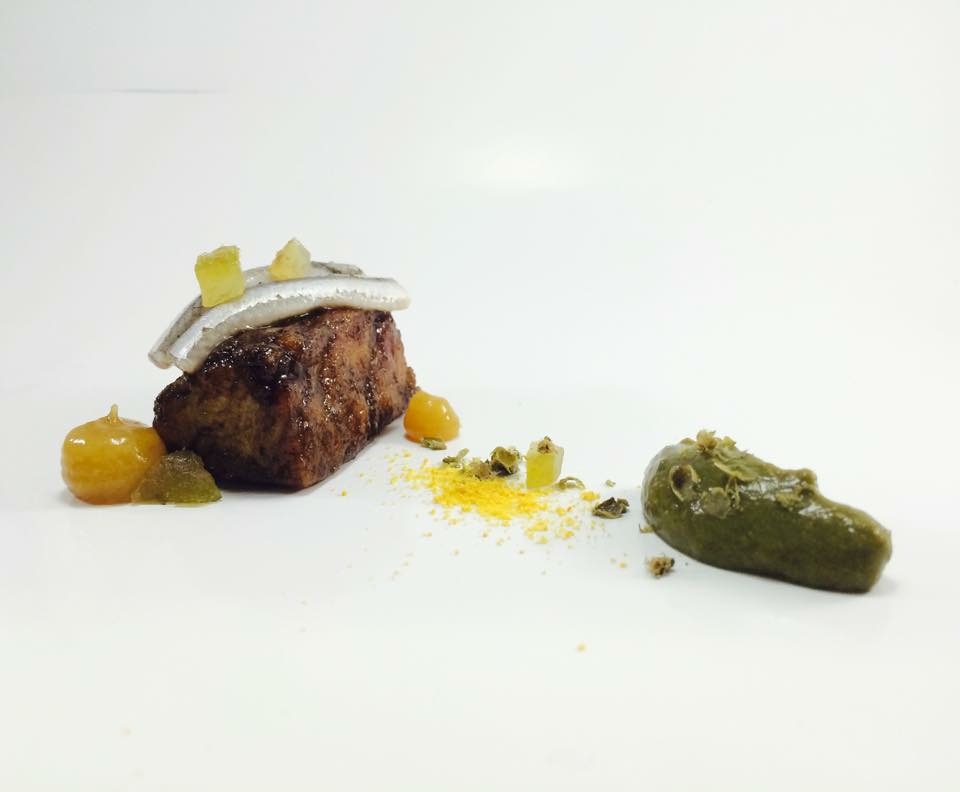 Photogallery






Gianni Dezio, Tosto, Atri (Teramo)

Tortelli with artichokes, fondue of pecorino from Atri, mint and liquorice. Liquorice and mint unite so as to enhance one of the most important vegetables in Italian cuisine









Valerio Centofanti, L'Angolo d'Abruzzo, Carsoli (L'Aquila)

Pappardelle with gelded lamb with pecorino from Alta Valle del Turano. The lamb is gelded before it is two months’ old and raised for 18 months. A dish full of emotions and sensations that has disappeared from Italian kitchens (in the picture, the gelded lamb)









Niko Romito, Reale Casadonna, Castel di Sangro (L'Aquila)

Because it’s the proof that constant research in the kitchen (in this case applied to cutting and macerating cabbage) can pull down the "wall" of vegetal representation and give new and powerful solutions in terms of structure and taste. Creating surprise and deep emotion. For me, it represents a new phase









Mattia Spadone, La Bandiera, Civitella Casanova (Pescara)

Vegetables cooked in salt. I worked on cooking in salt only using vegetables (from our kitchen garden). It may seem banal but I’ve been working on this for over 3 months: these are roots and leaves presented in different textures, crispy, mashed and thinly diced









Patrizia Corradetti, Zenobi, Colonnella (Teramo)

Meat and spinach ravioli with Neapolitan genovese sauce. I needed to include in the mid-August menu a first course with filled pasta that would still be traditional









Nadia Moscardi, Elodia nel Parco, L'Aquila

Textures of pasta and vegetable garden. It is inspired by Le Virtù, an ancient soup from Abruzzo that was made by the bride for the future mother-in-law to prove her virtues in the kitchen










William Zonfa, Magione Papale, L'Aquila

Castratissimo. Gelded meat is very popular in Abruzzo. The sauce you see is a dehydrated “veil of gelded meat sauce”, wrapping the soft meat. Upon contact with the heat and humidity of the meat, it is rehydrated and gives life to the memory of meat chops coming out from the sauce itself









Cinzia Mancini, Bottega Culinaria Biologica, San Vito Chietino (Chieti)

Pescatrice noir. My territory and the elements defining it: sun, rocks, sea, wind and fire









Stefania Di Pasquo, Locanda Mammì, Agnone (Isernia)

Raspberry mousse with caramelised white chocolate and hazelnuts. It’s a non-sweet sweet, a dessert that represents a change from the classic desserts I have in the menu. It represents my current desire for change









Felice Sgarra, Umami, Andria

Cream of cannellini beans and scampi with lemon sourness. A fresh course but also one that is suitable for every occasion
 









Antonio Scalera, La Bul, Bari

Home-smoked mackerel, toasted walnuts, jam and gelatine of friggitelli peppers. Blue tailed fish: poor, from the tradition and history of Apulia. Cinderella becomes the queen on our table









Giovanni Lorusso, Memory resort, Bisceglie (Barletta, Andria e Trani)

Sea bass, smoked Jerusalem artichoke, green affilla and sesame praliné. The fish, the aroma of almonds, the sauce of smoked Jerusalem artichoke, the aroma of the baby peas that have just sprouted and the sesame praliné adding sweetness and balsamic notes









Teresa Galeone Buongiorno, Già Sotto l'Arco, Carovigno (Brindisi)

Pink gnocchi with pesto heart, ricotta and puffed beetroot. A voluptuous mix of colours and flavours









Antonella Ricci and Vinod Sookar, Al Fornello da Ricci, Ceglie Messapica (Brindisi)

Drops of ricotta on a pesto of wild chards, crispy pancetta and pepper smoked with apple wood. The brackish note of the chards enhances the milky taste of the ricotta, strictly produced by Mrs Anna Argentiero. In this season there’s the best ricotta and wild chards. In the menu until April









Francesco Nacci, Botrus, Ceglie Messapica (Brindisi)

I wanted to be a chop. Smoked carpaccio with olive leaves where the "thinness" substitutes the "long cooking time" and the creams with classic flavours (tomato, pecorino, capers) give it the softness and succulence of a homemade "braciola al sugo" (chop with tomato sauce)
 









Filomena Silibello, Cibus, Ceglie Messapica (Brindisi)

Quail soup with simeto durum wheat, chicory and wild scattapietre. The hunting tradition of this territory and the richness of wild herbs induced our grandmothers to serve all that nature had to offer locally









Salvatore Amato, Borgo Valle Rita, Ginosa (Taranto)

Risotto with burnt garlic, oil, chilli pepper and sea urchins. Our agricultural tradition and all the elegance of the sea melt in a dish capable of recalling the best childhood memories









Alfredo De Luca, Malcandrino, Lecce

Risotto, sorbet of red onion from Tropea, chicken liver, radishes and wild fennel. The well-established match of onions and liver becomes an explosion thanks to rice









Angelo Sabatelli, Angelo Sabatelli, Monopoli (Bari)

Squid, allievo (baby squid), almond and lemon. A dish that encloses all of Apulia in 3 ingredients: squid (in two versions: the adult for the veil and the baby served raw), candied lemon from Gargano and cream of almonds from Toritto (photo by Lello D'Anna)









Pietro Zito, Antichi Sapori, Montegrosso (Andria) 

Black chard lasagne stuffed with pancotto with turnip tops and potatoes. For us, real farmers, who grew up in the old countryside, vegetarian and vegan cuisine were everyday life. A few days ago I introduced this deceivable dish in the menu: there’s no meat, no egg, no cheese. Still, it is good and looks good









Enzo Florio, Da Tuccino, Polignano a Mare (Bari)

Crispy red mullet with almonds. The aroma of the seaside in Apulia enclosed in a dish, plus potatoes from Polignano









Andrea Cannalire, Cielo del Relais La Sommità, Ostuni (Brindisi)

Egg and Flour (dedicated to my father). My father has a poultry farm and he still produces eggs and for me this was the biggest homage I could give him because he gave me the chance to become what I am today









Salvatore Carlucci, La Barca di Ciro, Pulsano (Taranto)
Oyster Coconut & Passion. It’s an oyster marinated in seawater, aromatised with ginger and pepper from Jamaica, immersed in fresh coconut milk and served with a passion fruit gel









Stefano Di Gennaro, Quintessenza, Trani

Red mullet, orange, carrot and sweet and sour onion. Straight to the essence of the sea and the deepness of the earth: eating the red mullet, one can perfectly sense the sea, the deepness of the earth refers to cultivating onions and carrots









Gaetano Servidio, Menelao a Santa Chiara, Turi (Bari)

Cream of chickpeas from Altamura with chargrilled king trumpet mushrooms and pastry with smoked scamorza. A historic dish at our restaurant: strong and clear flavours, a rustico that gets rid of technique (which as chefs we always seek obsessively). It encloses the warmth of the people of Apulia









Gianfranco Bruno, Lo Scrigno dei Sapori alle Masserie del Falco, Forenza (Potenza)

La podolica in transumanza. That is to say slowly-cooked cheek of podolica cow, mousse of fennels, hazelnuts and black tea with mandarin. The journey of a podolica cow – a typical meat from Basilicata, used for stews – which acquires new scents and textures






