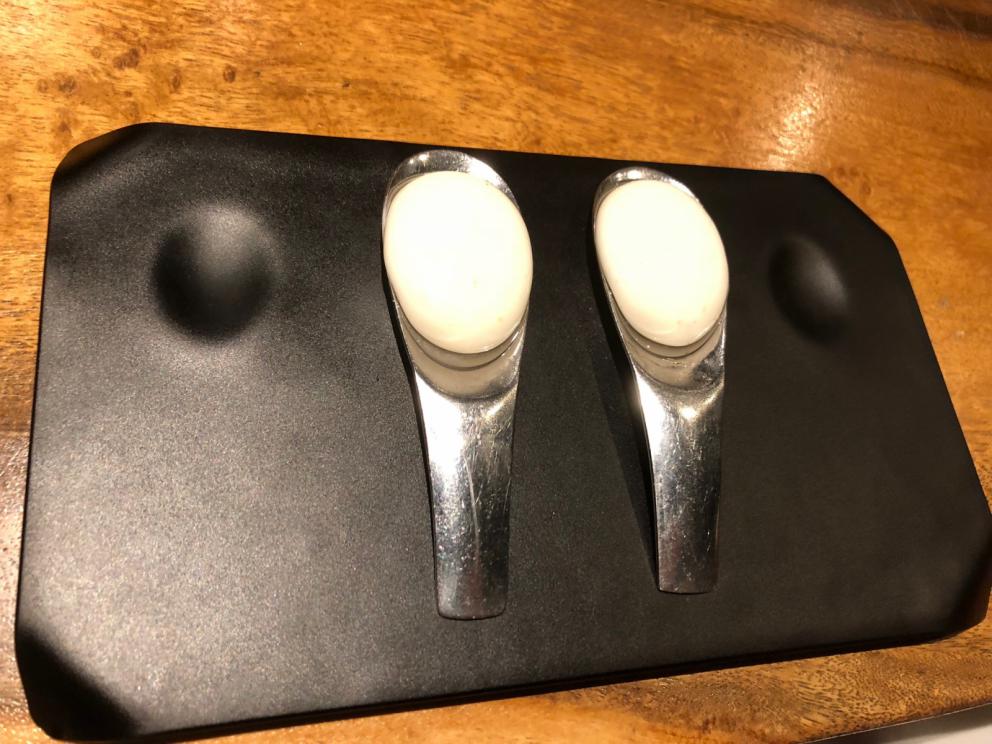 Photogallery






The sign appearing on Soi Langsuan in Bangkok, the little road where you can find restaurant Gaggan and, in front of it, the new-born Gaa, same ownership









The entrance to the restaurant, which recently got the second Michelin star. It’s open only in the evening. There are 65 people here who serve 100 clients daily, divided into two shifts (photo from themalaymailonline.com)









Gaggan’s famous emoji menu: "We first create the dish, then we sum it up with an emoji", he points out (photo from Andershusa/Instagram)









1 
Pink elderflower and watermelon
The tasting menu starts with the notes of the Foo Fighters. The entire first part of the menu is to be eaten with your hands: "This is how it works in India", he explains. First dish: a pearl among elderberry flowers and watermelon in an edible oyster shell. A debut to rinse the palate






