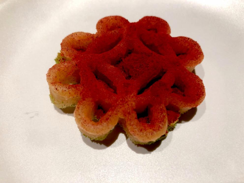 Photogallery






The sign appearing on Soi Langsuan in Bangkok, the little road where you can find restaurant Gaggan and, in front of it, the new-born Gaa, same ownership









The entrance to the restaurant, which recently got the second Michelin star. It’s open only in the evening. There are 65 people here who serve 100 clients daily, divided into two shifts (photo from themalaymailonline.com)









Gaggan’s famous emoji menu: "We first create the dish, then we sum it up with an emoji", he points out (photo from Andershusa/Instagram)









1 
Pink elderflower and watermelon
The tasting menu starts with the notes of the Foo Fighters. The entire first part of the menu is to be eaten with your hands: "This is how it works in India", he explains. First dish: a pearl among elderberry flowers and watermelon in an edible oyster shell. A debut to rinse the palate









2
Yogurt Explosion
Gaggan’s most famous dish. It’s the result of his early internship at elBulli in Roses, Catalonia. "If Ferran Adrià has had Spanish people accept a spherified olives", he says, "why shouldn’t I do the same with an emblem of India?". The spherified yogurt is made with low fat yogurt dipped in a sodium alginate









3
Lick it up. Mushroom peas
With "Lick it up", a hit from the Eighties by Kiss playing in the background, they serve this dish which you must hold with both hands and lick. The sauces, from bottom to top, in "licking order ": tomato, dehydrated mushrooms and mashed green chickpeas. On top, shaved truffle.  "Music, words, food. This is how we represent lightness"









Gaggan holds a cone









4
Tom Yum Kung
This is his version of Tom Yam (or Yum), a popular Thai soup. It’s a cold purée of tom yam served in crispy rice paper with a head of scampi to add flavour. It’s a sort of prawn cocktail in the shape of a cone






