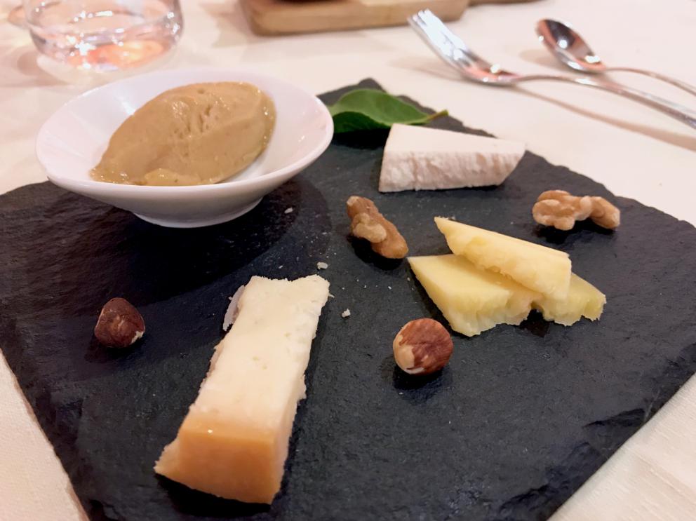 Galleria fotograficaBattuto di Bruno sarda, ricotta affumada e pane di patate
Pane con la lingua cotta in acqua salmistrata, aceto di Cannonau. Una delizia
Panada alla salsiccia
Coniglio a succhittu, sfumato con la Vernaccia: la sella con i suoi fegatini, un crumble di pane alle erbe, olivelle del Campidano e crema di carote. Gran piatto
Lumache in umido piccante, schiacciata di patate, &laquo;una ricetta di mio padre, realizzata in tegame&raquo;
Zichi di Bonorva cotto nel brodo&nbsp;di pecora&nbsp;con carne di pecora, &laquo;un piatto 100% tradizione&raquo;, e buonissimo. Lo Zichi &egrave; un tipico pane sardo originario di Bonorva, nella Sardegna settentrionale.
Elegantissimi, soavi i Tortelli di gallina alla maggiorana e pomodori appassiti. La gallina &egrave; ruspante di montagna, il piatto condito con olio agrumato
Favolosa la Lonza di pecora al sangue, marinata con le erbe, more di rovo e mandorle. Piatto perfetto. &laquo;Aggiungo le stesse more mangiate dalle pecore allo stato brado&raquo;
