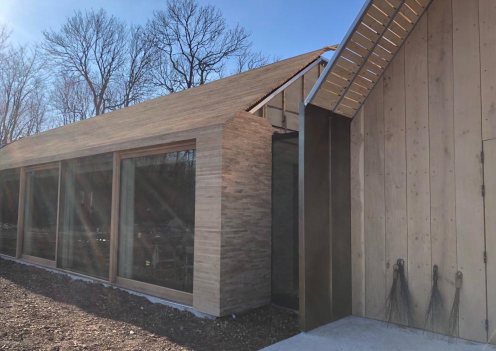 Photogallery






Noma 2.0 is in Christianshavn, the same neighbourhood as the first Noma. They’re 1.5 km apart, a 15 minutes’ walk. This picture shows the distance: to the right, there’s the warehouse of the old location (in Strandgade 93), to the left the smokestacks of Amager Bakke, the futuristic incinerator below which stands the new Noma (in Refshalevej 96)









Weather permitting, you can have a peaceful walk between the previous Noma to today’s Noma 









The new Noma is on an isthmus surrounded by canals. In the future they also want to reclaim some small parts for hydroponic farming









Bucolic scene with incinerator









Bikes left outside Noma. It’s the favourite means of transport among employees and interns









The long path taking you to the restaurant. The fence on the left shows how works are still in progress









On the two sides of the path there are the two new sections of the "Noma village", each with its specialty: grill, hot dishes, snacks, fermentations... In one month’s time, behind the fence we’ll have greenhouses, the test kitchen and the bread making area









To the left, before arriving at the restaurant, the future test kitchen. This will be run by Danish Mette Søberg with Riccardo Canella. "My first challenge?", reveals the latter, for a long time sous chef here, "is to work on the extraction of essential oils" 









The future Test Kitchen









The temporary gangway to the restaurant









Looking from the door to the restaurant, there’s a lake and the smokestacks puffing vapour from the Amager Bakke incinerator. It’s a futuristic project, both in terms of sustainability and architecture. It’s also known as Amager Slope or Copenhill, and its author is starchitect Bjarke Ingels, the same who designed the new Noma. Gradually opened in 2017, it transforms waste into electricity. The goal is to donate electricity to 62500 houses and hot water to 160000. It’s part of an ambitious project to transform Copenhagen into the first city in the world in terms of zero carbon dioxide emissions by 2025. By autumn this year, Amager Slope should open its ski slope, a climbing wall and a hiking track. You’ll be able to slalom on top of the incinerator






