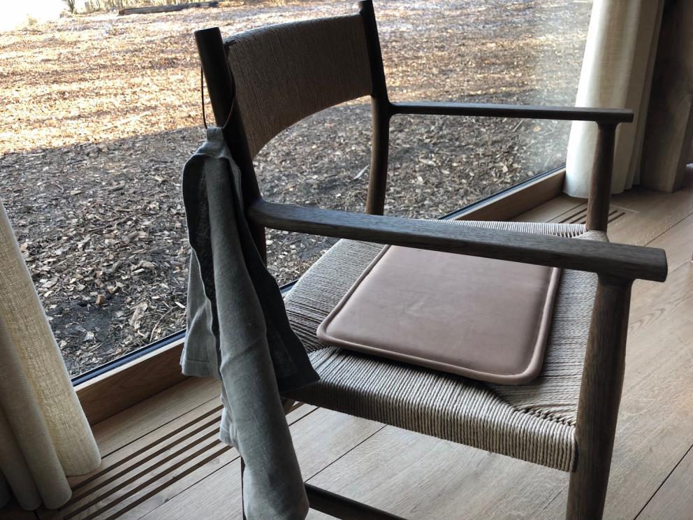 Photogallery






Noma 2.0 is in Christianshavn, the same neighbourhood as the first Noma. They’re 1.5 km apart, a 15 minutes’ walk. This picture shows the distance: to the right, there’s the warehouse of the old location (in Strandgade 93), to the left the smokestacks of Amager Bakke, the futuristic incinerator below which stands the new Noma (in Refshalevej 96)









Weather permitting, you can have a peaceful walk between the previous Noma to today’s Noma 









The new Noma is on an isthmus surrounded by canals. In the future they also want to reclaim some small parts for hydroponic farming









Bucolic scene with incinerator









Bikes left outside Noma. It’s the favourite means of transport among employees and interns









The long path taking you to the restaurant. The fence on the left shows how works are still in progress









On the two sides of the path there are the two new sections of the "Noma village", each with its specialty: grill, hot dishes, snacks, fermentations... In one month’s time, behind the fence we’ll have greenhouses, the test kitchen and the bread making area









To the left, before arriving at the restaurant, the future test kitchen. This will be run by Danish Mette Søberg with Riccardo Canella. "My first challenge?", reveals the latter, for a long time sous chef here, "is to work on the extraction of essential oils" 









The future Test Kitchen









The temporary gangway to the restaurant









Looking from the door to the restaurant, there’s a lake and the smokestacks puffing vapour from the Amager Bakke incinerator. It’s a futuristic project, both in terms of sustainability and architecture. It’s also known as Amager Slope or Copenhill, and its author is starchitect Bjarke Ingels, the same who designed the new Noma. Gradually opened in 2017, it transforms waste into electricity. The goal is to donate electricity to 62500 houses and hot water to 160000. It’s part of an ambitious project to transform Copenhagen into the first city in the world in terms of zero carbon dioxide emissions by 2025. By autumn this year, Amager Slope should open its ski slope, a climbing wall and a hiking track. You’ll be able to slalom on top of the incinerator









The windows from the dining room









Work is still in progress (photo taken on Thursday 22nd February 2018)









Traces of the old building, with barbwire. During WWII, they built bombs here









A view of the dining room at night (photo from Instagram/James Spreadbury)









The entrance to the restaurant









The usual ritual: a welcome from the entire staff, led by Rene Redzepi 









Behind the entrance, there are formaldehyde tanks with creatures from the abyss, shaped as in Damien Hirst’s works. The first image once you’re inside is to reproduce a Scandinavian village









The service kitchen is larger, more spacious and a completely open view from the dining room: "It’s the heart of our Scandinavian village", says Canella. There are 30 cooks working here now. 10 more, compared to the previous Noma









Large skylights above the cooks









There are currently more than 100 people working at Noma, of whom 63 are cooks - 26 employed, and 37 as interns









There’s fire in the kitchen, for the first time









On average, the dining room can host 40 people. "However", complains Redzepi, "there’s always someone who turns up with more people than the ones booked"









While the dining room is set, the outside space still need to be defined









The staff made the dining room decorations. There are no overly expensive designer objects









Dried fish









Seaweeds hanging from the ceiling









Dried octopus heads preserved in salt (with a balloon inside)














Bjarke Ingels and Redzepi’s plan included the wish to recreate a Danish farm









The luminous private dining room









The counter in the dining room. They drew the beams from the canals around the restaurant














The mise en place, bare and strictly without tablecloths









Water jug, candle, flower vase









A warm cloth, to begin with









Australian James Spreadbury, restaurant manager and partner at Noma









Welcome drink: Champagne extra brut Blanc d'Argile from Domaine Vouette et Sorbée









Sea Snail broth. The welcome dish at Noma is, as usual, a hot “soup”









Stefano Ferrano, from Torino, presents the following dish. There’s always a large Italian colony at Noma









Venus clams. Molluscs from Limfjord (Denmark) mixed with decorative clams, typical of Noma. Beside them, shells with blackcurrant oil and “Danish curry”, made with toasted coriander seeds, fennel and fennel seeds









The lid above the following dish. The mussels are not edible









Best of the mussel. Mussels open in a pan with water of fermented barley. «We recreate the mussel», says Canella, «using just the flaps, the best part». The paste is made with scraps from the mussel, cooked in smoked butter









The next dish is conceived and served by Riccardo Canella, the Paduan sous chef who conquered Redzepi, here with dining room intern Feline Hansen









Dried fruits and shrimps. In this case, the heads are not a decoration, but you must suck them –best not eat them because of the bones: they’re filled with a lovely prawn cream. The small crustaceans are still alive when they arrive on a ship straight from the Norwegian fjords









Inside, under the prawn broth skin, there’s fruits and vegetable preserved from the previous summer with raw prawns and gooseberry sauce with blackcurrant oil









How about beverages? There are three options, as usual: wine pairing (6 glasses plus a beer plus sake, 150 euros), juice pairing (juices and extracts, 110 euros) or a choice from the list. They recommend Champagne Chut... Libre from Val'Frison pour Dominique Derain, 50% Pinot Noir, 50% Chardonnay created by a couple who met at the old Noma. Well bodied, it will be a good match throughout the meal









As usual, the wine list starts with Champagne: the cheapest is 1400 crowns (190 euros)









White wines begin with labels from cold climates: first Austria, increasingly popular for its natural wines, then Germany, then all the others









How about Italy? Few names, among the white wines, from North and South









A dozen red/orange wines









Sea star, that is to say Cured trout roe and eggs, the emblem dish of this new era. They recommend moving the teaspoon from the heart to the edges of the tentacles. Aesthetics win over taste









Jellyfish. The jellyfish gel in the middle is in fact a clarified broth of calamari and recalls the texture of jellyfish. "We tried to cook jellyfish in 300 different ways but none was convincing so far". All around, pickled seaweed. The gel is almost tasteless, it serves to clean the palate after the pickles









Rene Redzepi himself presents the content of the first Seafood platter.









French style service with a small plate below for the empty shells









It’s made of two (per two) pieces: queen clam and mahogany clam









The Queen Clam is a very small variety of Norwegian scallop, seasoned with a vegetal reduction made with cucumber and peas miso. The red tip is the coral. "You should eat it using the top shell ", recommends Redzepi









The Mahogany clam is a centennial clam from the North Sea, very popular in Denmark and Iceland. «You can tell the age by the number of rings, like with trees», says Redzepi, «In 2007 they found one that was 450 years old. We’ve had it in the menu for a decade or so». The razor clam shell serves as teaspoon









Inside, there’s obviously not just a bare Mahogany. «We open it when the client arrives», says Canella, «remove the entrails and then slice it so as to preserve its firm texture». It’s seasoned with stir-fried gooseberry, capers of blackcurrants and blackcurrant sprouts preserved in vinegar. The sauce is made with mussel water






